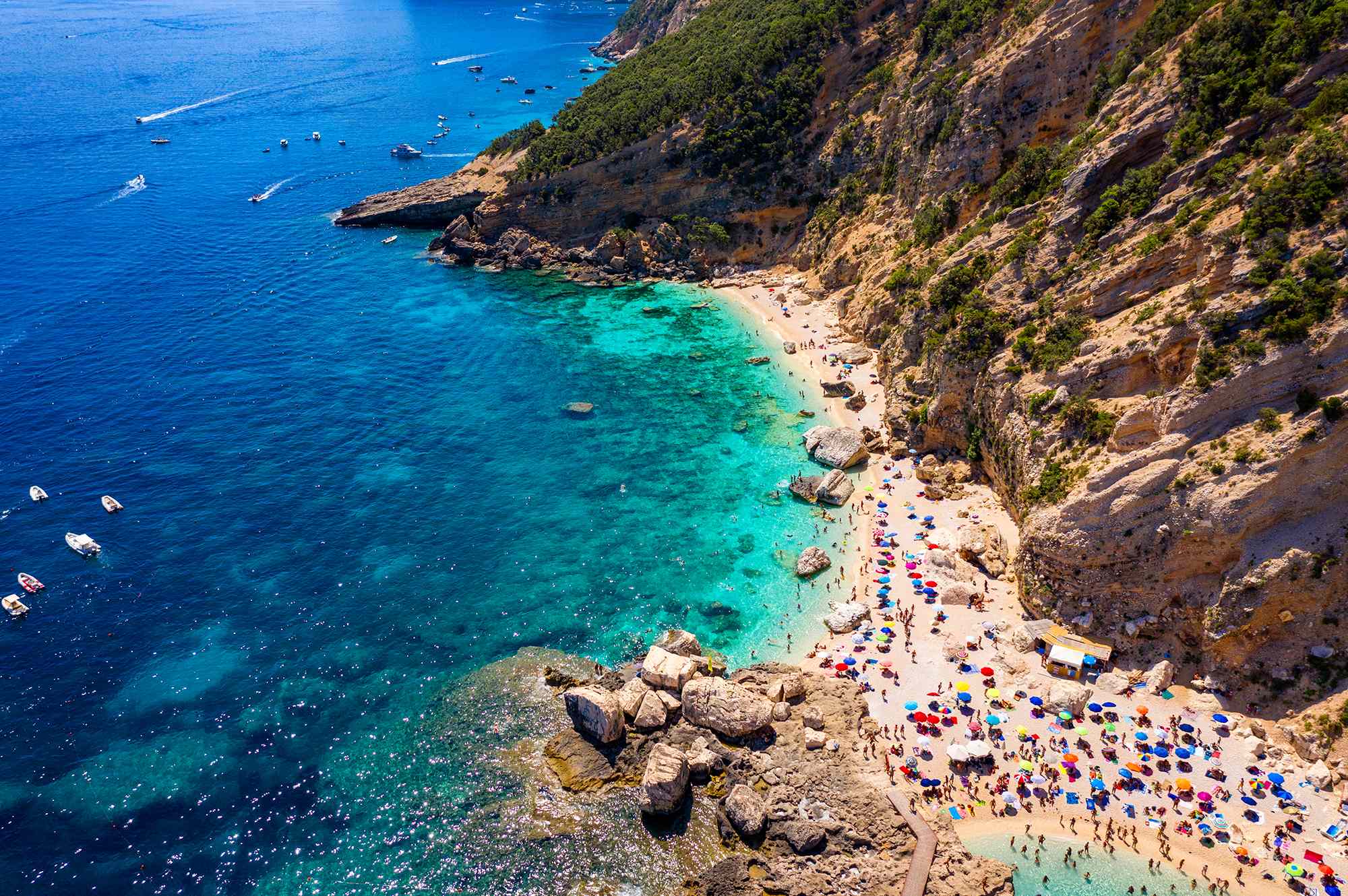 This Italian Beach Was Named One of the World’s Most Beautiful—and It’s Only Reachable by Boat or Foot #Travel Cala Mariolu is the perfect day trip when visiting the island of Sardinia.