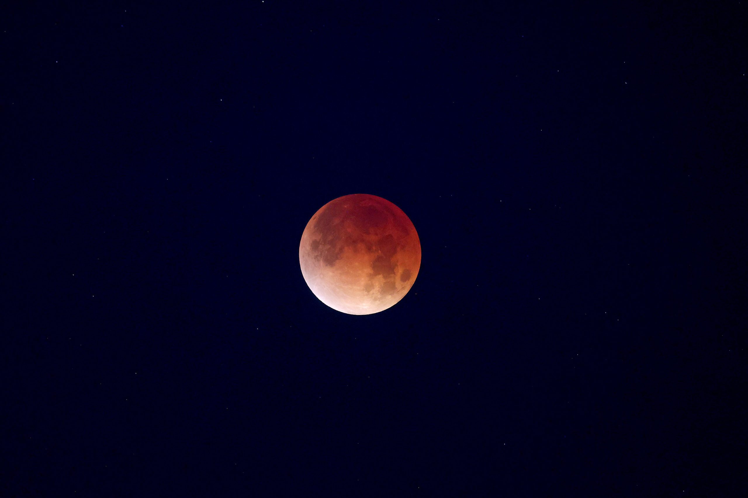 Total Lunar Eclipse – A total lunar eclipse rises over New Orleans, home of NASA’s Michoud Assembly Facility, in the early morning hours of Tuesday, March 3. A lunar eclipse occurs when Earth passes directly between the Sun and Moon, casting a huge shadow across the Moon’s surface. The Moon appears dark red or orange as the Sun’s light filters through Earth’s atmosphere.