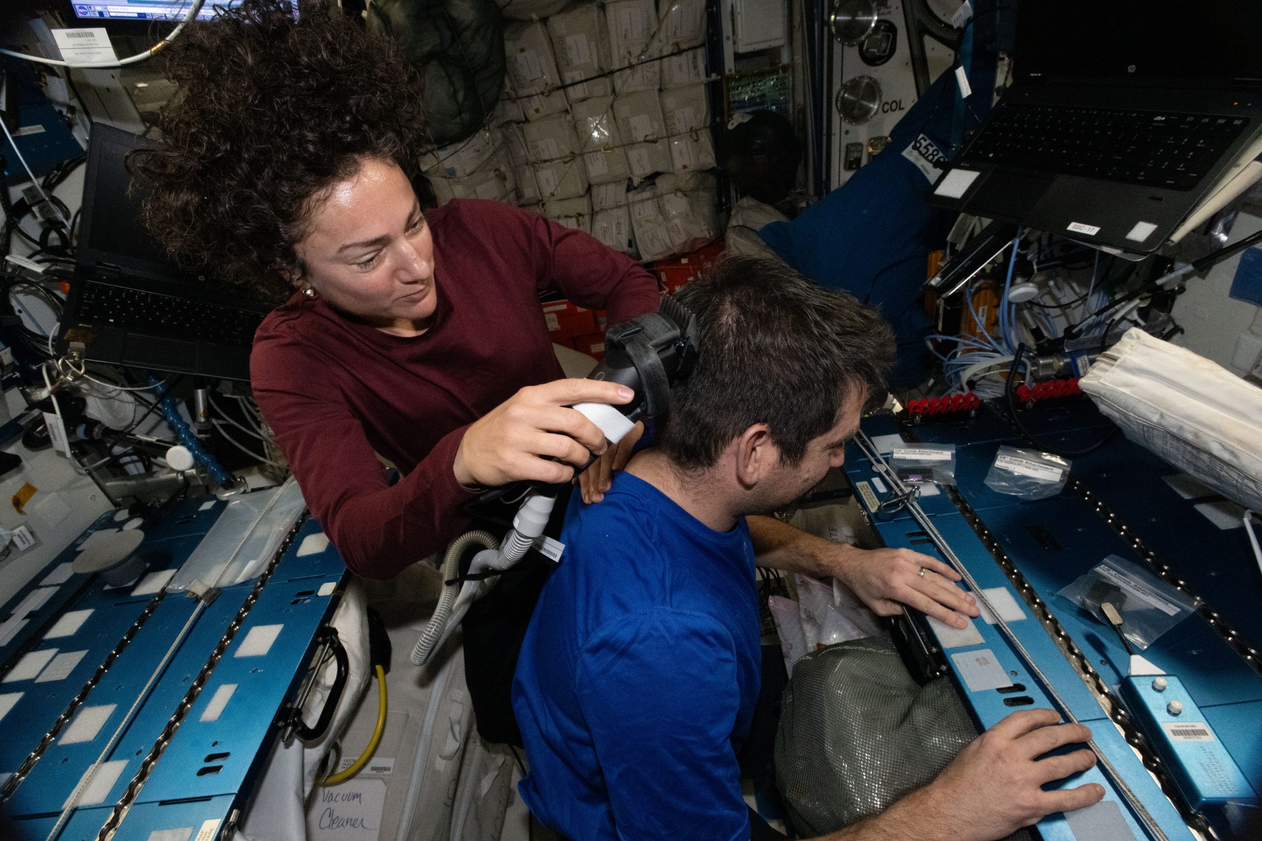 Weekends on the Space Station – Weekends on the International Space Station are for housecleaning and haircuts. NASA astronaut Jessica Meir trims the hair of fellow NASA astronaut Jack Hathaway, both Expedition 74 flight engineers, using an electric razor attached to a vacuum that collects loose clippings to keep the station’s atmosphere clean in microgravity.