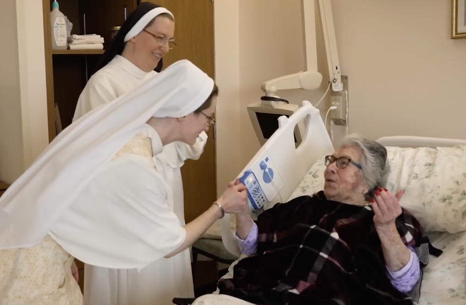 Dominican Sisters challenge New York gender-identity law in court – #Catholic – A group of Catholic religious sisters has taken care of terminal cancer patients free of charge in New York for almost 125 years without a problem.Now, state officials are warning the sisters and other nursing home administrators about restricting rooms and bathrooms to one sex and failing to use preferred personal pronouns for patients who identify as transgender. The state is also requiring public postings of an antidiscrimination notice.The Dominican Sisters of Hawthorne, who operate Rosary Hill Home, a 42-bed facility, have received three letters from the state’s public health agency, including one warning about “refusing to assign a room to a resident other than in accordance with the resident’s gender identity,” “prohibiting a resident from using a restroom available to other persons of the same gender identity,” and “willfully and repeatedly failing to use a resident’s preferred name or pronouns after being clearly informed of the preferred name or pronouns.”The letters took the sisters off guard; a state agency’s website shows zero complaints against Rosary Hill Home, located in Hawthorne, a hamlet in the Westchester County town of Mount Pleasant, about 30 miles northeast of Manhattan.But complying with the state’s rules is not an option for them, since the directives contradict their Catholic faith, the sisters told the National Catholic Register, the sister partner of EWTN News.The Catholic Church teaches that sex can’t be changed or separated from gender, although it also says people identifying as transgender must be treated with respect and compassion.“I think the most important thing is that we are adamant in keeping our Catholic identity. Without that, there’s no purpose for us to do what we’re doing,” Mother Marie Edward, OP, the superior of the religious congregation, told the Register.
Entrance to the Rosary Hill Home, a 42-bed facility located in Westchester County, about 30 miles northeast of Manhattan in New York. | Credit: “EWTN Pro-Life Weekly”/Screenshot
The sisters filed a lawsuit against the state on Monday, claiming the state is violating their rights under the First Amendment of the U.S. Constitution.The lawsuit, filed in U.S. District Court for the Southern District of New York in White Plains, names as defendants New York Gov. Kathy Hochul and four state administrators in the New York State Department of Health. All are sued in their official capacity.The complaint claims that the state is violating the sisters’ freedom of speech by requiring them to state a point of view they don’t agree with and their free exercise of religion by requiring them to make statements against their Catholic faith.The complaint also notes that the state statute appears to exempt institutions run by the Church of Christ, Scientist — it doesn’t apply to those “whose teachings include reliance on spiritual means through prayer alone for healing” — which the complaint says violates the Catholic sisters’ religious freedom by favoring one religion over another.A spokesman for the governor did not respond to a request for comment by publication of this story.Cadence Acquaviva, senior public information officer for the New York State Department of Health, also contacted by the Register, emailed the Register the following statement: “While the department does not comment on pending or ongoing litigation, the department is committed to following state law, which provides nursing home residents certain rights protecting against discrimination including, but not limited to, gender identity or expression.”New York lawThe letters to the sisters from the state’s public health agency stem from a statute that the New York Legislature passed in 2023 with little fanfare and almost no opposition, known as “The Long-Term Care Facility Residents’ Bill of Rights for LGBTQIA+ New Yorkers and People Living with HIV.”The state Legislature’s website shows no public hearing for the bill that created the law. When it was introduced on the floor of the lower chamber, the New York State Assembly, in June 2023, the bill drew questions from three Republicans over the course of about 10 minutes, mostly informational and none hostile. Religious liberty did not come up.The Assembly passed the bill 144-2. The New York Senate passed the bill 55-7. Hochul signed the bill into law on Nov. 30, 2023, the eve of World AIDS Day.“New York’s seniors should be able to live their lives with the dignity and respect they deserve, free from discrimination of every kind,” Hochul said, according to a press release issued by her office at the time. “LGBTQIA + and HIV-positive seniors are among our most vulnerable populations, and today we are taking steps to ensure that all New Yorkers — regardless of who they are, who they love, or their HIV status — find safety and support in places where they need it the most. Hate will never have a place in New York.”The sisters told the Register they had never heard of the bill until the letters from the state started arriving about two years ago. State officials have not taken steps against the sisters, but the sisters say they’re worried that they will.“Over 125 years, as far as they know, they’ve never once had a patient who was wanting to make the gender journey, to transition. And that’s significant, because why are we going through this?” said L. Martin Nussbaum, the sisters’ lawyer and a partner with First & Fourteenth, a law firm with an office in Colorado Springs, Colorado, in an interview. “This law imposed on the Dominican Hawthorne Sisters is a form of gender ideology virtue signaling, to require these sisters to be trained in an ideology entirely contrary to Catholic belief.”“Why are we doing this? We don’t even have such patients,” Nussbaum said. “It’s the state requiring these holy nuns to bend the knee to an ideology contrary to their faith.”One letter from the state warned the sisters that their nursing home can’t “restrict a resident’s right to associate with other residents or with visitors, including the right to consensual expression of intimacy or sexual relations, unless the restriction is uniformly applied to all residents in a nondiscriminatory manner.”Rosary Hill Home belongs to the Catholic Benefits Association, which advocates for free exercise of religion rights of members in providing employee benefits. Nussbaum, who represents the association, said the state’s gender-identity requirements are creating a problem where there was none.“The sisters do not want to litigate. They want this resolved, and they want to focus on their ministry,” Nussbaum said.The congregationThe Dominican Sisters of Hawthorne was founded by Mother Mary Alphonsa, who was known as Rose Hawthorne Lathrop (1851–1926) before she entered religious life. She was one of three children of the 19th-century novelist Nathaniel Hawthorne, author of “The House of the Seven Gables” and “The Scarlet Letter.”Raised Unitarian, Rose converted to Catholicism during the 1890s. In 1896, she opened an apartment on the Lower East Side of Manhattan for patients with incurable cancer.
The foundress of the Dominican Sisters of Hawthorne, Mother Mary Alphonsa, was the daughter of the renowned 19th-century American writer Nathaniel Hawthorne. | Credit: “EWTN Pro-Life Weekly”/Screenshot
“I set my whole being to endeavor to bring consolation to the cancerous poor,” she later wrote, according to a biography of her on the congregation’s website.She founded a religious congregation in 1900, which opened a nursing home in Hawthorne, New York, in June 1901.Pope Francis in March 2024 declared her venerable, which is two steps below canonization. Her cause needs a miracle to proceed to beatification and another to qualify her to be declared a saint.The congregation currently has 44 sisters, split between New York and another nursing facility in Atlanta called Our Lady of Perpetual Help Home.In the New York facility, about 14 sisters tend to sick patients with the help of lay certified nursing assistants, sisters told the Register.The home has no limit on the length of stay, and some patients stay for years, sisters told the Register, though the average stay is about two to three months. The vast majority of patients who come to the nursing home die there.‘We’ve given our life to God’The New York facility was the subject of an admiring photographic essay and short article in The New York Times Magazine in May 2016, spearheaded by a photographer who appreciated the care the sisters had given to her Jewish mother-in-law when she was dying of cancer.Mother Marie Edward, who joined the congregation in 1979, told the Register that living their Catholic faith and witnessing to it to others are essential for the sisters, whose work is only partly about taking care of the sick.“Nursing is a marvelous work in and of itself, but our sisters are, we’re all consecrated, we’ve taken vows, we’ve given our life to God, and certainly prayer is utmost, primary. That we consider a work, and the sisters live a very enclosed life of prayer first, and then it spills over into the care of the patients, so that we are to care for the patients as if they were Christ, the suffering Christ,” she said.“And to do that, we have to be very strong in our identity as Christians, and to follow the teachings of Christ,” she added. “So to do something that goes contrary to that, it just wouldn’t work.”The superior general cited John 14:6 as one of the reasons the sisters can’t treat males as if they were females, or vice versa.“Christ is the center, and the Eucharist sustains us. But Christ is also, as he said, the way, the truth, and the life. And if he’s the truth, then we cannot practice what we do, incorporating something that is an untruth,” she explained.“And it is an untruth to say that a male should go into a female patient’s room. You’re just trying to contort things, for whatever reason. So we have to stand by the truth of what has been taught to us in the natural law. It is not to be changed,” Mother Marie Edward said.“For us, this is what sustains us,” added Sister Stella Mary, the superior of Rosary Hill Home, who joined in 2006.“This is our strength. If our faith wasn’t there, the type of care we provide would not be the same,” she said.“I’m not saying that other people cannot do so, but the things and the environment that permeates in this place is very different because of our faith, because Christ is here present in the Eucharist,” she continued.“And anybody that comes in here will always say how peaceful it feels in here, the difference from any other place that they’ve been to,” she said. “So I think there is no way we could do what we do day in and day out, with the difficulties that caring for the sick means, without having our faith.”Nussbaum, the congregation’s lawyer, told the Register that the state’s requirements on gender identity pose an existential threat to the nursing home, because both the home and the staff members who work there need to renew their licenses under state rules.The Register asked the sisters if they are concerned that the state might force their nearly 125-year-old nursing home to shut down if they don’t comply.“I’m not really worried, because I know the Lord is going to take care of us,” Mother Marie Edward said.This story was first published by the National Catholic Register, the sister partner of EWTN News, and has been adapted by EWTN News. Dominican Sisters challenge New York gender-identity law in court – #Catholic – A group of Catholic religious sisters has taken care of terminal cancer patients free of charge in New York for almost 125 years without a problem.Now, state officials are warning the sisters and other nursing home administrators about restricting rooms and bathrooms to one sex and failing to use preferred personal pronouns for patients who identify as transgender. The state is also requiring public postings of an antidiscrimination notice.The Dominican Sisters of Hawthorne, who operate Rosary Hill Home, a 42-bed facility, have received three letters from the state’s public health agency, including one warning about “refusing to assign a room to a resident other than in accordance with the resident’s gender identity,” “prohibiting a resident from using a restroom available to other persons of the same gender identity,” and “willfully and repeatedly failing to use a resident’s preferred name or pronouns after being clearly informed of the preferred name or pronouns.”The letters took the sisters off guard; a state agency’s website shows zero complaints against Rosary Hill Home, located in Hawthorne, a hamlet in the Westchester County town of Mount Pleasant, about 30 miles northeast of Manhattan.But complying with the state’s rules is not an option for them, since the directives contradict their Catholic faith, the sisters told the National Catholic Register, the sister partner of EWTN News.The Catholic Church teaches that sex can’t be changed or separated from gender, although it also says people identifying as transgender must be treated with respect and compassion.“I think the most important thing is that we are adamant in keeping our Catholic identity. Without that, there’s no purpose for us to do what we’re doing,” Mother Marie Edward, OP, the superior of the religious congregation, told the Register.
Entrance to the Rosary Hill Home, a 42-bed facility located in Westchester County, about 30 miles northeast of Manhattan in New York. | Credit: “EWTN Pro-Life Weekly”/Screenshot
The sisters filed a lawsuit against the state on Monday, claiming the state is violating their rights under the First Amendment of the U.S. Constitution.The lawsuit, filed in U.S. District Court for the Southern District of New York in White Plains, names as defendants New York Gov. Kathy Hochul and four state administrators in the New York State Department of Health. All are sued in their official capacity.The complaint claims that the state is violating the sisters’ freedom of speech by requiring them to state a point of view they don’t agree with and their free exercise of religion by requiring them to make statements against their Catholic faith.The complaint also notes that the state statute appears to exempt institutions run by the Church of Christ, Scientist — it doesn’t apply to those “whose teachings include reliance on spiritual means through prayer alone for healing” — which the complaint says violates the Catholic sisters’ religious freedom by favoring one religion over another.A spokesman for the governor did not respond to a request for comment by publication of this story.Cadence Acquaviva, senior public information officer for the New York State Department of Health, also contacted by the Register, emailed the Register the following statement: “While the department does not comment on pending or ongoing litigation, the department is committed to following state law, which provides nursing home residents certain rights protecting against discrimination including, but not limited to, gender identity or expression.”New York lawThe letters to the sisters from the state’s public health agency stem from a statute that the New York Legislature passed in 2023 with little fanfare and almost no opposition, known as “The Long-Term Care Facility Residents’ Bill of Rights for LGBTQIA+ New Yorkers and People Living with HIV.”The state Legislature’s website shows no public hearing for the bill that created the law. When it was introduced on the floor of the lower chamber, the New York State Assembly, in June 2023, the bill drew questions from three Republicans over the course of about 10 minutes, mostly informational and none hostile. Religious liberty did not come up.The Assembly passed the bill 144-2. The New York Senate passed the bill 55-7. Hochul signed the bill into law on Nov. 30, 2023, the eve of World AIDS Day.“New York’s seniors should be able to live their lives with the dignity and respect they deserve, free from discrimination of every kind,” Hochul said, according to a press release issued by her office at the time. “LGBTQIA + and HIV-positive seniors are among our most vulnerable populations, and today we are taking steps to ensure that all New Yorkers — regardless of who they are, who they love, or their HIV status — find safety and support in places where they need it the most. Hate will never have a place in New York.”The sisters told the Register they had never heard of the bill until the letters from the state started arriving about two years ago. State officials have not taken steps against the sisters, but the sisters say they’re worried that they will.“Over 125 years, as far as they know, they’ve never once had a patient who was wanting to make the gender journey, to transition. And that’s significant, because why are we going through this?” said L. Martin Nussbaum, the sisters’ lawyer and a partner with First & Fourteenth, a law firm with an office in Colorado Springs, Colorado, in an interview. “This law imposed on the Dominican Hawthorne Sisters is a form of gender ideology virtue signaling, to require these sisters to be trained in an ideology entirely contrary to Catholic belief.”“Why are we doing this? We don’t even have such patients,” Nussbaum said. “It’s the state requiring these holy nuns to bend the knee to an ideology contrary to their faith.”One letter from the state warned the sisters that their nursing home can’t “restrict a resident’s right to associate with other residents or with visitors, including the right to consensual expression of intimacy or sexual relations, unless the restriction is uniformly applied to all residents in a nondiscriminatory manner.”Rosary Hill Home belongs to the Catholic Benefits Association, which advocates for free exercise of religion rights of members in providing employee benefits. Nussbaum, who represents the association, said the state’s gender-identity requirements are creating a problem where there was none.“The sisters do not want to litigate. They want this resolved, and they want to focus on their ministry,” Nussbaum said.The congregationThe Dominican Sisters of Hawthorne was founded by Mother Mary Alphonsa, who was known as Rose Hawthorne Lathrop (1851–1926) before she entered religious life. She was one of three children of the 19th-century novelist Nathaniel Hawthorne, author of “The House of the Seven Gables” and “The Scarlet Letter.”Raised Unitarian, Rose converted to Catholicism during the 1890s. In 1896, she opened an apartment on the Lower East Side of Manhattan for patients with incurable cancer.
The foundress of the Dominican Sisters of Hawthorne, Mother Mary Alphonsa, was the daughter of the renowned 19th-century American writer Nathaniel Hawthorne. | Credit: “EWTN Pro-Life Weekly”/Screenshot
“I set my whole being to endeavor to bring consolation to the cancerous poor,” she later wrote, according to a biography of her on the congregation’s website.She founded a religious congregation in 1900, which opened a nursing home in Hawthorne, New York, in June 1901.Pope Francis in March 2024 declared her venerable, which is two steps below canonization. Her cause needs a miracle to proceed to beatification and another to qualify her to be declared a saint.The congregation currently has 44 sisters, split between New York and another nursing facility in Atlanta called Our Lady of Perpetual Help Home.In the New York facility, about 14 sisters tend to sick patients with the help of lay certified nursing assistants, sisters told the Register.The home has no limit on the length of stay, and some patients stay for years, sisters told the Register, though the average stay is about two to three months. The vast majority of patients who come to the nursing home die there.‘We’ve given our life to God’The New York facility was the subject of an admiring photographic essay and short article in The New York Times Magazine in May 2016, spearheaded by a photographer who appreciated the care the sisters had given to her Jewish mother-in-law when she was dying of cancer.Mother Marie Edward, who joined the congregation in 1979, told the Register that living their Catholic faith and witnessing to it to others are essential for the sisters, whose work is only partly about taking care of the sick.“Nursing is a marvelous work in and of itself, but our sisters are, we’re all consecrated, we’ve taken vows, we’ve given our life to God, and certainly prayer is utmost, primary. That we consider a work, and the sisters live a very enclosed life of prayer first, and then it spills over into the care of the patients, so that we are to care for the patients as if they were Christ, the suffering Christ,” she said.“And to do that, we have to be very strong in our identity as Christians, and to follow the teachings of Christ,” she added. “So to do something that goes contrary to that, it just wouldn’t work.”The superior general cited John 14:6 as one of the reasons the sisters can’t treat males as if they were females, or vice versa.“Christ is the center, and the Eucharist sustains us. But Christ is also, as he said, the way, the truth, and the life. And if he’s the truth, then we cannot practice what we do, incorporating something that is an untruth,” she explained.“And it is an untruth to say that a male should go into a female patient’s room. You’re just trying to contort things, for whatever reason. So we have to stand by the truth of what has been taught to us in the natural law. It is not to be changed,” Mother Marie Edward said.“For us, this is what sustains us,” added Sister Stella Mary, the superior of Rosary Hill Home, who joined in 2006.“This is our strength. If our faith wasn’t there, the type of care we provide would not be the same,” she said.“I’m not saying that other people cannot do so, but the things and the environment that permeates in this place is very different because of our faith, because Christ is here present in the Eucharist,” she continued.“And anybody that comes in here will always say how peaceful it feels in here, the difference from any other place that they’ve been to,” she said. “So I think there is no way we could do what we do day in and day out, with the difficulties that caring for the sick means, without having our faith.”Nussbaum, the congregation’s lawyer, told the Register that the state’s requirements on gender identity pose an existential threat to the nursing home, because both the home and the staff members who work there need to renew their licenses under state rules.The Register asked the sisters if they are concerned that the state might force their nearly 125-year-old nursing home to shut down if they don’t comply.“I’m not really worried, because I know the Lord is going to take care of us,” Mother Marie Edward said.This story was first published by the National Catholic Register, the sister partner of EWTN News, and has been adapted by EWTN News.