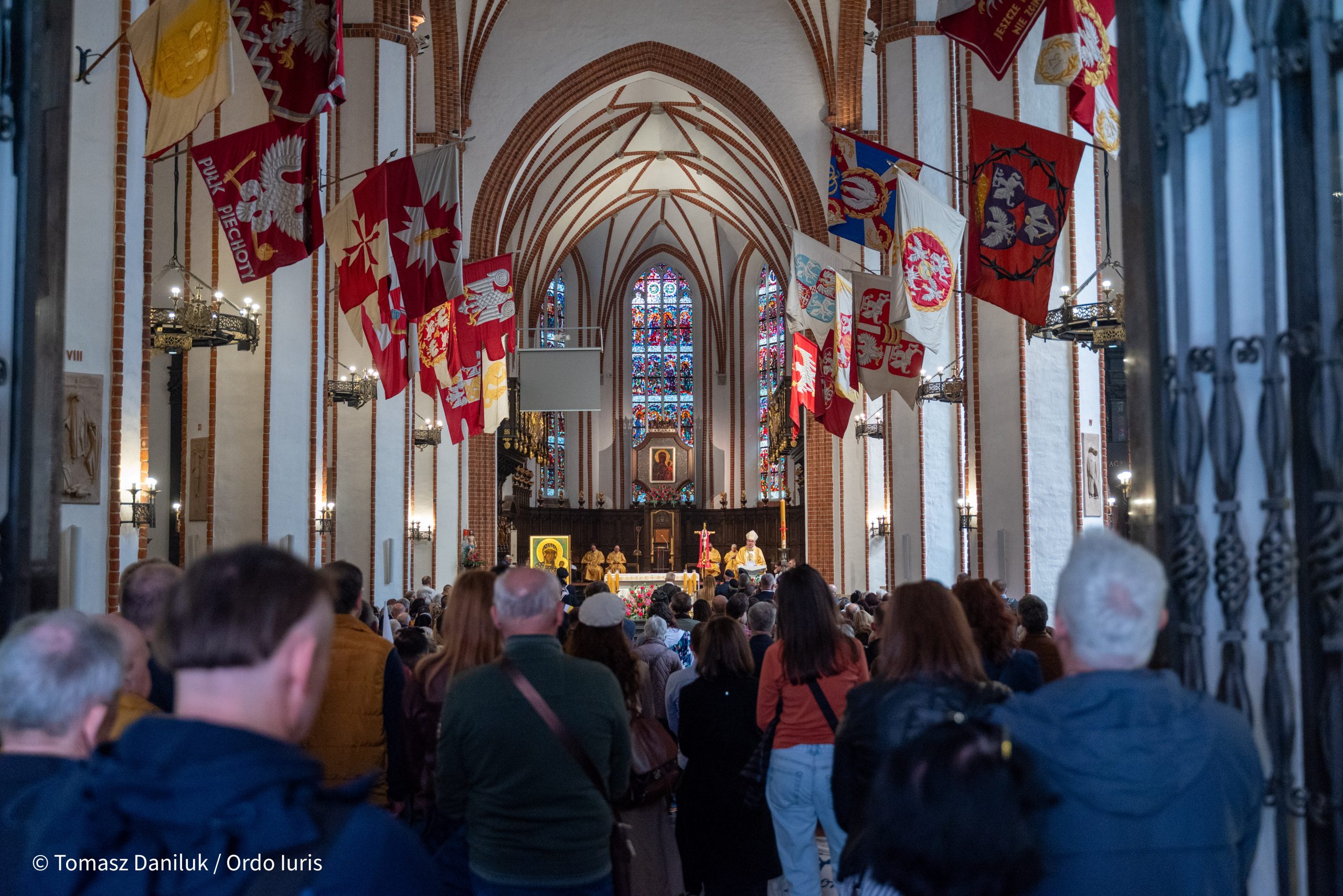 March for Life in Warsaw commemorates 1,060 years of Christianity in Poland #Catholic Thousands of people gathered in Poland’s capital on April 19 for the National March for Life, a large public demonstration organized under the slogan “Faith and Fidelity 1966–2026,” commemorating the 1,060th anniversary of the Christianization of Poland. The event combined religious observance, civic participation, and pro-life advocacy, drawing families, clergy, activists, and public figures to central Warsaw. The day began with Mass celebrated in two of the cityʼs major churches. 
 
 Mass is celebrated at the Archcathedral Basilica of the Martyrdom of St. John the Baptist in Warsaw, Poland, on April 19, 2026. | Credit: Tomasz Daniluk/Ordo Iuris
 
 In the Archcathedral Basilica of St. John the Baptist, Bishop Piotr Jarecki presided over the liturgy, while Bishop Tomasz Sztajerwald celebrated Mass at the Cathedral of St. Michael the Archangel and St. Florian in Warsaw-Praga.Participants later gathered at Castle Square, where the march officially began. Organizers described the event as a public expression of support for life and family, rooted in Poland’s Christian tradition. Metropolitan Archbishop Adrian Galbas of Warsaw encouraged participation ahead of the event, framing it as a testimony to human dignity. “We want to testify that we are lovers of life. Bring your family along! Life triumphs over every death,” he declared.
 
 Church leaders join Poland’s President Karol Nawrocki and other dignitaries at the March for Life in Warsaw on April 19, 2026. | Credit: Tomasz Daniluk/Ordo lures
 
 March through Warsaw highlights pro-life messageThe procession moved through central Warsaw streets under the historic slogan marking Poland’s Christian heritage. As participants approached the Presidential Palace, Polish President Karol Nawrocki spoke, linking the march to broader social concerns.“I support initiatives that serve Poland, and this initiative certainly serves Poland,” he said. “It is also a response to the deep demographic crisis. Today, the answer to many Polish problems lies precisely in Polish families, in our identity, in remembering where we come from and where we are going.”Organizers said the march was intended not only as a demonstration of pro-life conviction but also as a broader reflection on national identity and social cohesion.A prominent symbol carried during the march was a copy of the icon of Our Lady of Częstochowa, which has been traveling internationally for 14 years as part of the From Ocean to Ocean pilgrimage in defense of life. The icon has traveled more than 220,000 kilometers (almost 137,000 miles) and visited 32 countries across five continents.
 
 Participants carry an icon of Our Lady of Częstochowa. | Credit: Tomasz Daniluk/Ordo Iuris
 
 Shifting abortion attitudes among younger PolesThe National March for Life is organized by the St. Benedict Foundation alongside dozens of pro-life groups from across Poland and takes place under the honorary patronage of the Polish Episcopal Conference.Patrycja Michońska-Dynek, director of the Press Center of the Archdiocese of Warsaw, told EWTN News that there are shifting public attitudes toward abortion in Poland, including growing societal acceptance and increased calls for liberalization, attributing these changes to secularization, cultural pressures, and differing interpretations of freedom.Michońska-Dynek also observed that while pro-life values remain important in Polish society, younger generations often approach the issue with more nuanced perspectives, particularly in complex or exceptional situations. Fostering a “culture of life” must include practical support for families, such as assistance for single mothers and couples in crisis, Michońska-Dynek said.
 
 Lidia, a participant at the National March for Life. | Credit: Tomasz Daniluk/Ordo Iuris
 
 Not a single-issue agendaLidia Sankowska-Grabczuk, one of the organizers of the National March for Life, told EWTN News that the pro-life movement in Poland extends beyond a single-issue focus on abortion.“In a nutshell, the pro-life movement is [often] the anti-abortion movement. In our view… it’s a bit different. We don’t reduce it to a single-issue agenda,” she said, warning that such a narrow framing “strips it of its true meaning.” While protecting unborn life remains central, she described it as part of a broader vision rooted in what she called “the public voice of Polish Christianity.”She outlined three core pillars underpinning the movement. The first is “respect for life,” encompassing not only the unborn but also solidarity with the elderly, families, and those in need. The second is the family as society’s foundation, grounded in the traditional understanding of marriage and its role in Poland’s social stability. The third pillar is “a state serving the common good,” reflecting a view of politics as service and a call for greater social solidarity.
 
 March for Life in Warsaw commemorates 1,060 years of Christianity in Poland. | Credit: Tomasz Daniluk/Ordo Iuris
 
 Sankowska-Grabczuk also discussed the importance of Poland’s historical and Christian identity in shaping the movement. She noted that recent marches have intentionally marked major national milestones, including the 1,000th anniversary of Poland’s first royal coronation in 2025.These commemorations, she said, highlight how the movement sees its mission as inseparable from Poland’s historical development, where Christianity has long informed both national identity and social values.Pro-life voices and public participationAmong international participants was Tonio Borg, president of the European Federation One of Us. He urged participants to remain steadfast in their convictions despite criticism or public pressure. “Do not be afraid of being slandered and ridiculed because you seek to protect life from the moment of conception,” he said, encouraging continued public engagement and advocacy. He also called on supporters to make their voices heard in the public sphere, stressing the importance of influencing lawmakers and demonstrating that “the unborn child is one of us.”
 
 Paula, a participant at the National March for Life in Poland. | Credit: Tomasz Daniluk/Ordo Iuris
 
 Marcin Perłowski, director of the Centre for Life and Family, said participants gathered at the march out of a shared conviction that “human life begins at conception” and must be defended. He stated that the National March for Life serves as a public demonstration of that belief, describing it as a stand “against all those who raise a hand against unborn children.”Pro-life activist Emilia Mędrzecka told EWTN News that her position is grounded in a belief in universal human dignity. “Children in the womb are as human as we are… they are more dependent and need time to grow,” she said while adding that the march reflected a strong presence of families, young people, and older generations united in support of life.
 
 Polish president Karol Nawrocki walks among participants at the National March for Life in Poland. | Credit: Tomasz Daniluk/Ordo Iuris
 
 While official attendance figures have not been released, estimates provided to EWTN News suggested more than 10,000 people participated, with organizers placing peak attendance between 25,000 and 30,000.
