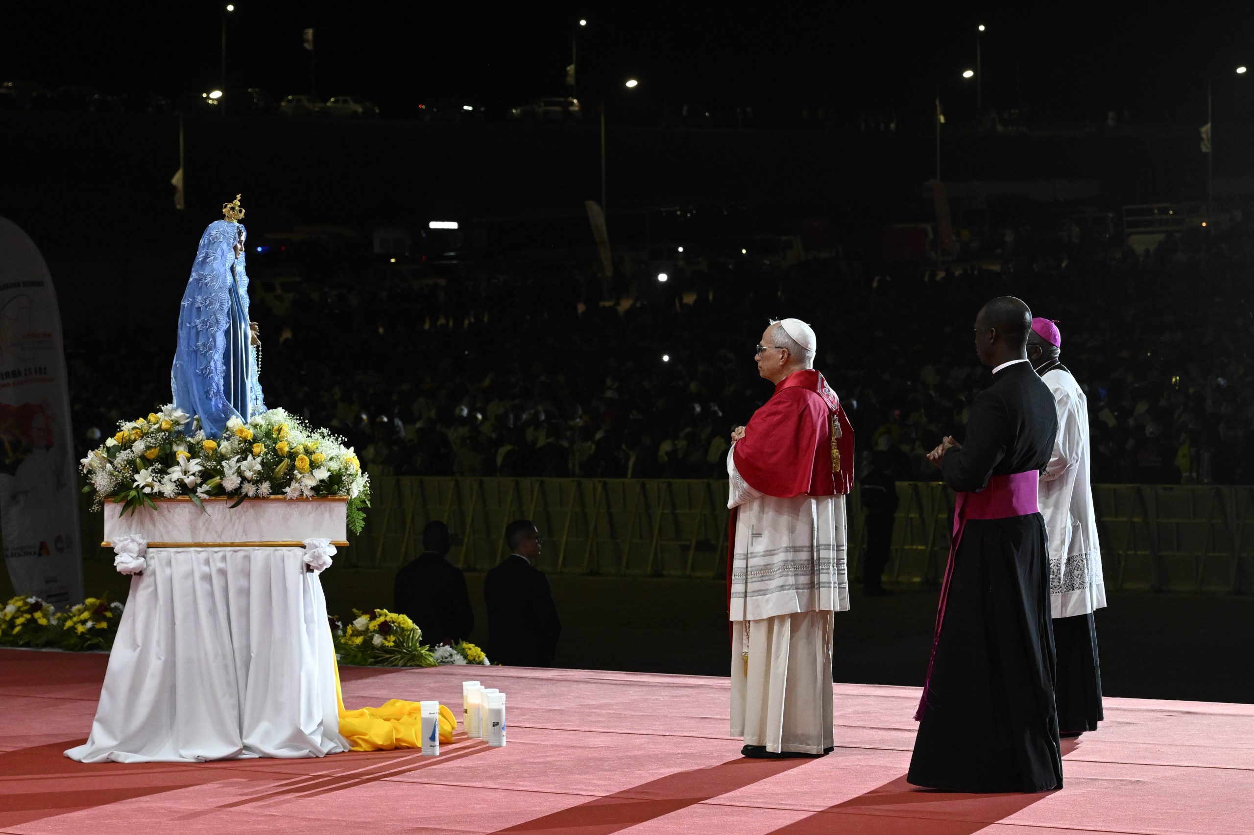 PHOTOS: Pope Leo XIV celebrates Mass, leads rosary in Angola – #Catholic – Pope Leo XIV continued his apostolic journey in Africa on April 19 in Angola, celebrating Mass in Kilamba before leading the rosary in a gathering at the Marian shrine of Mama Muxima.Addressing young people, members of the Legion of Mary, and other pilgrims gathered at the shrine, the pope said he was “pleased to share this moment of Marian prayer” with them.Here are some of the highlights of Pope Leo’s activities on Sunday:
 
 Pope Leo XIV waves to crowds gathered before Mass in Kilamba, Angola, on April 19, 2026. | Credit: Vatican Media
 

 
 Pope Leo XIV makes the sign of the cross at the beginning of Mass in Kilamba, Angola, on April 19, 2026. | Credit: Vatican Media
 

 
 Pope Leo XIV celebrates Mass in Kilamba, Angola, on April 19, 2026. About 100,000 faithful packed the large esplanade where the Eucharistic celebration took place. | Credit: Vatican Media
 

 
 Pope Leo XIV celebrates Mass in Kilamba, Angola, on April 19, 2026. | Credit: Vatican Media
 

 
 Pope Leo XIV incenses the altar during Mass in Kilamba, Angola, on April 19, 2026. | Credit: Vatican Media
 

 
 Pope Leo XIV looks out the window during his ride to the Marian shrine of Mama Muxima in Kimbaxe, Angola, on April 19, 2026. | Credit: Vatican Media
 

 
 Pope Leo XIV waves to crowds gathered to pray the rosary at the Marian shrine of Mama Muxima in Kimbaxe, Angola, on April 19, 2026. | Credit: Vatican Media
 

 
 Pope Leo XIV greets a baby during his visit to the Marian shrine of Mama Muxima in Kimbaxe, Angola, on April 19, 2026. | Credit: Vatican Media
 

 
 Pope Leo XIV lays flowers at the Marian shrine of Mama Muxima in Kimbaxe, Angola, on April 19, 2026. | Credit: Vatican Media
 

 
 Pope Leo XIV prays at the Marian shrine of Mama Muxima in Kimbaxe, Angola, on April 19, 2026. | Credit: Vatican Media
 

 
 Pope Leo XIV leads the rosary at the Marian shrine of Mama Muxima in Kimbaxe, Angola, on April 19, 2026. | Credit: Vatican Media
 

 
 Crowds gather to pray the rosary with Pope Leo XIV at the Marian shrine of Mama Muxima in Kimbaxe, Angola, on April 19, 2026. | Credit: Vatican Media