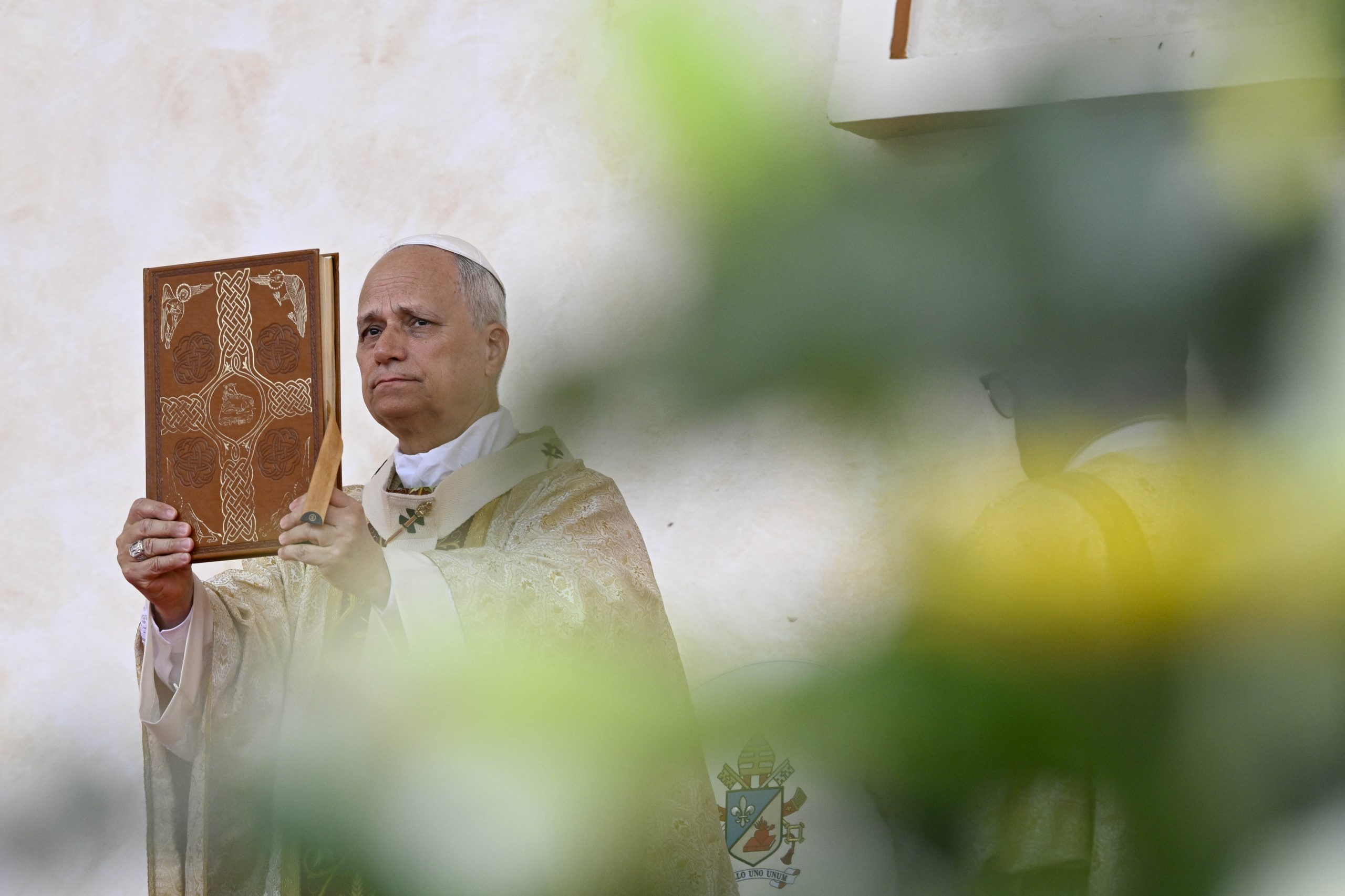 PHOTOS: Pope Leo XIV departs Africa, returns to Rome after 11-day papal trip – #Catholic – Pope Leo XIV departed Africa and returned to Rome on April 23, concluding an 11-day visit to several countries that marked his first visit as pope to the continent. The Holy Father departed Equatorial Guinea after saying Mass at the coastal nationʼs Malabo Stadium. He had earlier visited Algeria, Cameroon, and Angola throughout mid-April. Hereʼs a look at Leo XIVʼs departure from Africa and return home: 
 
 Pope Leo XIV waves from the popemobile at Malabo Stadium in Equatorial Guinea, Thursday, April 23, 2026. | Credit: Vatican Media
 

 
 Catholics smile during Mass with Pope Leo XIV at Malabo Stadium in Equatorial Guinea, Thursday, April 23, 2026. | Credit: Vatican Media
 

 
 Pope Leo XIV greets the faithful during Mass at Malabo Stadium in Equatorial Guinea, Thursday, April 23, 2026. | Credit: Vatican Media
 

 
 Pope Leo XIV greets a family during Mass at Malabo Stadium in Equatorial Guinea, Thursday, April 23, 2026. | Credit: Vatican Media
 

 
 Pope Leo XIV holds the chalice aloft during Mass at Malabo Stadium in Equatorial Guinea, Thursday, April 23, 2026. | Credit: Vatican Media
 

 
 Pope Leo XIV presides over Mass at Malabo Stadium in Equatorial Guinea, Thursday, April 23, 2026. | Credit: Vatican Media
 

 
 Crowds pray the Mass with Pope Leo XIV at Malabo Stadium in Equatorial Guinea, Thursday, April 23, 2026. | Credit: Vatican Media
 

 
 Pope Leo XIV stands beneath a towering crucifix during Mass at Malabo Stadium in Equatorial Guinea, Thursday, April 23, 2026. | Credit: Vatican Media
 

 
 Pope Leo XIV views a statue of the Virgin Mother and Christ Child at Malabo Stadium in Equatorial Guinea, Thursday, April 23, 2026. | Credit: Vatican Media
 

 
 Pope Leo XIV participates in a farewell ceremony at the Malabo International Airport in Equatorial Guinea before leaving the country to fly back to Rome at the conclusion of his 11-day Africa trip on April 23, 2026. | Credit: Vatican Media
 

 
 Pope Leo XIV speaks aboard the papal plane from Malabo, Equatorial Guinea, to Rome, following an 11-day trip in Africa, April 23, 2026. | Credit: Patrick Leonard/EWTN News
 

 
 Pope Leo XIV speaks to journalists aboard the papal plane to Rome, Thursday, April 23, 2026. | Credit: Vatican Media
