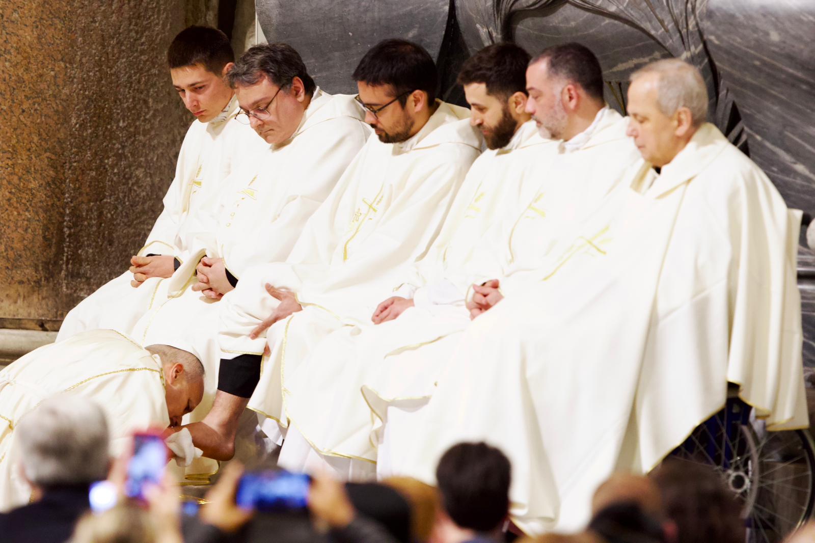 Pope Leo XIV: ‘Kneel down as brothers and sisters alongside the oppressed’ #Catholic Pope Leo XIV on Holy Thursday returned the Mass of the Lord’s Supper to the Basilica of St. John Lateran, reviving a papal practice last observed there in 2012 under Benedict XVI.Departing from Pope Francis’ custom of celebrating the liturgy in prisons or migrant centers, Leo celebrated the rite in the cathedral of Rome and washed the feet of 12 priests of the Diocese of Rome.In his homily, the pope framed the liturgy as the solemn entrance into the Easter Triduum and said Christ’s love, shown in both the Eucharist and the washing of the feet, reveals the justice of God in a world wounded by evil.“This evening’s solemn liturgy marks our entry into the holy Triduum of the Lord’s passion, death, and resurrection,” Leo said. “We cross this threshold not as mere spectators, nor out of habit, but as those personally invited by Jesus himself as guests at the Supper in which bread and wine become for us the sacrament of salvation.”“His love becomes both gesture and nourishment for all, revealing the justice of God,” the pope said. “In this world, and particularly in those places where evil abounds, Jesus loves definitively — forever, and with his whole being.”Reflecting on the washing of the feet, Leo said the gesture is not simply a moral lesson but a revelation of God’s own way of loving.“What the Lord shows us — taking the water, the basin, and the towel — is far more than a moral example,” he said. “He entrusts to us his very way of life. The washing of the feet is a gesture that encapsulates the revelation of God.”The pope also cited Benedict XVI, recalling that Christians must repeatedly learn that God’s greatness is unlike worldly greatness. “We too must ‘learn repeatedly that God’s greatness is different from our idea of greatness… because we systematically desire a God of success and not of the Passion,’” Leo said.He warned that human beings are tempted to seek a God who grants success, victory, or usefulness like wealth and power rather than recognizing the divine power revealed in humble service.“Yet we fail to perceive that God does indeed serve us through the gratuitous and humble gesture of washing feet,” Leo said. “This is the true omnipotence of God.”The pope said Jesus’ action purifies both humanity’s false image of God and its false image of man.“For we tend to consider ourselves powerful when we dominate, victorious when we destroy our equals, great when we are feared,” he said. “In contrast, as true God and true man, Christ offers us the example of self-giving, service, and love.”Leo stressed that Christ gave this example not in a moment of acclaim but “on the night he was betrayed, in the darkness of incomprehension and violence.”“In this way, it becomes clear that the Lord’s love precedes our own goodness or purity; he loves us first, and in that love, he forgives and restores us,” the pope said.Quoting St. John’s Gospel, Leo urged Christians to live out mutual service in imitation of Christ: “He does not ask us to repay him but to share his gift among ourselves: ‘You also ought to wash one another’s feet.’”The pope also referred to Pope Francis’ 2013 Holy Thursday homily, noting that Christian service cannot be reduced to abstraction or empty obligation but must spring from charity.Allowing oneself to be served by the Lord, Leo said, is a precondition for serving others. “By washing our bodies, Jesus purifies our souls,” he said. “In him, God has given us an example — not of how to dominate, but of how to liberate; not of how to destroy life, but of how to give it.”In one of the homily’s strongest appeals, the pope turned to the suffering of those crushed by violence and oppression.“As humanity is brought to its knees by so many acts of brutality, let us too kneel down as brothers and sisters alongside the oppressed,” he said.Leo said the liturgy of Holy Thursday draws together the institution of the Eucharist and holy orders, revealing “the perfect self-gift of Jesus, the High Priest and living, eternal Eucharist.”Addressing priests directly, he said: “Beloved brothers in the priesthood, we are called to serve the people of God with our whole lives.”He concluded by inviting Catholics to spend time in Eucharistic adoration and to ask for the grace to imitate Christ’s love.“Holy Thursday is therefore a day of fervent gratitude and authentic fraternity,” the pope said. “May this evening’s Eucharistic adoration, in every parish and community, be a time to contemplate Jesus’ gesture, kneeling as he did, and to ask for the strength to imitate his service with the same love.”This story was first published by ACI Stampa, the Italian-language sister service of EWTN News. It has been translated and adapted by EWTN News English.