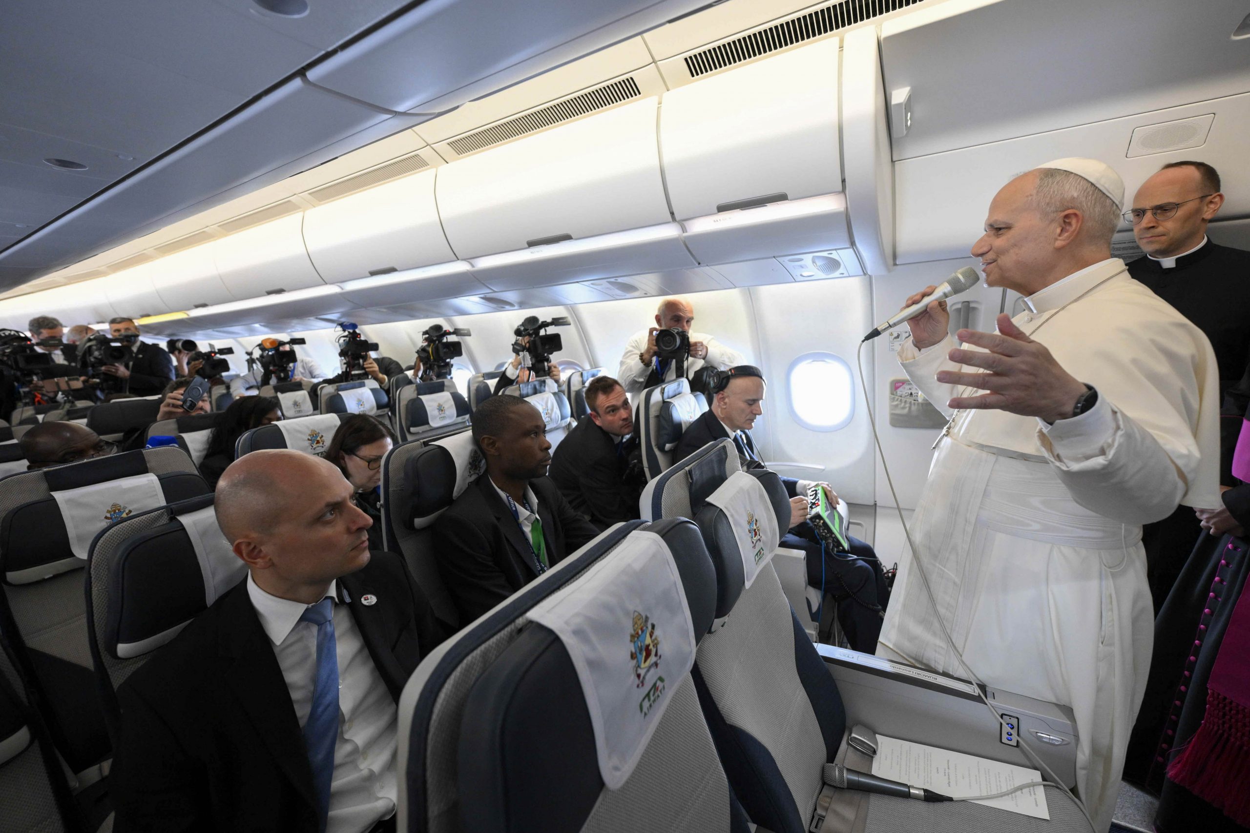 Pope Leo XIV says debate with Trump is ‘not in my interest at all’ #Catholic ABOARD THE PAPAL PLANE — Pope Leo XIV arrived in Angola after a two-and-a-half-hour flight from Cameroon on April 18, using the short journey to reject suggestions that his recent remarks about war were aimed at U.S. President Donald Trump while reflecting on the pastoral focus of his African trip.In a brief in-flight press conference with journalists, the pope addressed the interpretation of some of his recent speeches as a response to criticism from Trump, who had accused him of weakness in foreign policy.“[T]hereʼs been a certain narrative that has not been accurate in all of its aspects, but because of the political situation created when on the first day of the trip, the President of the United States made some comments about myself,” the pope said.“Much of what has been written since then has been more commentary on commentary, trying to interpret what has been said.”He pointed in particular to his address at the April 16 prayer meeting for peace in Cameroon.“Just one little example, the talk that I gave at the prayer meeting for peace a couple days ago was prepared two weeks ago, well before the president ever commented on myself and on the message of peace that I am promoting,” he said.“And yet, as it happens, it was looked at as if I was trying to debate again the president, which is not in my interest at all.”Leo XIV said he intends instead to continue proclaiming the Gospel and promoting peace.“So we go on the journey, we continue proclaiming the Gospel message,” he said.He added that the liturgies during the trip have highlighted what it means to follow Christ, promote fraternity, and seek justice and peace.The pope also said the broader African journey has been shaped by themes that emerged at the start of the trip in Algeria, especially the figure of St. Augustine.“I was personally very pleased, as you know, we began the trip in Algeria with the theme of Saint Augustine, and yesterday at the Catholic University, we had the blessing of that beautiful monument that they had prepared with a map of Africa and Saint Augustine at the center,” he said.“And so in one sense, it expresses part of what this trip is about.”Leo XIV emphasized that his primary purpose in Africa is to accompany Catholics.“And I primarily come to Africa as pastor, as the head of the Catholic Church, to be with, to celebrate with, to encourage and accompany all of the Catholics throughout Africa.”He also referred to a meeting with imams in Cameroon, describing it in general terms as part of the Church’s continuing commitment to interreligious dialogue, understanding, and peace-building.He concluded his main remarks by thanking journalists for their work and expressing hope that God would continue to bless the journey.Responding later to a French journalist, Leo XIV expressed gratitude for the reception he received in Cameroon.“I would just like to thank everyone in Cameroon for the wonderful welcome, the great enthusiasm, the joy of the people,” he said.“It was absolutely fantastic, the experience … how wonderful it is to experience what it means to be a follower of Jesus Christ and to celebrate our faith together.”The pope’s flight took him from Yaoundé to Luanda, crossing over Cameroon, Equatorial Guinea, Gabon, the Democratic Republic of Congo, and Angola. Angola is the third and penultimate stop of his African journey.The Catholic Church has longstanding ties with Angola. Formal relations date back centuries, including the 1608 appointment of Antonio Manuel Nyunda as the first ambassador to Rome from the then-Kingdom of Kongo. More recently, in 2019, the Holy See and Angola signed an agreement recognizing the legal personality of the Catholic Church and defining its property rights.This story was first published by ACI Stampa, the Italian-language sister service of EWTN News. It has been translated and adapted by EWTN News English.