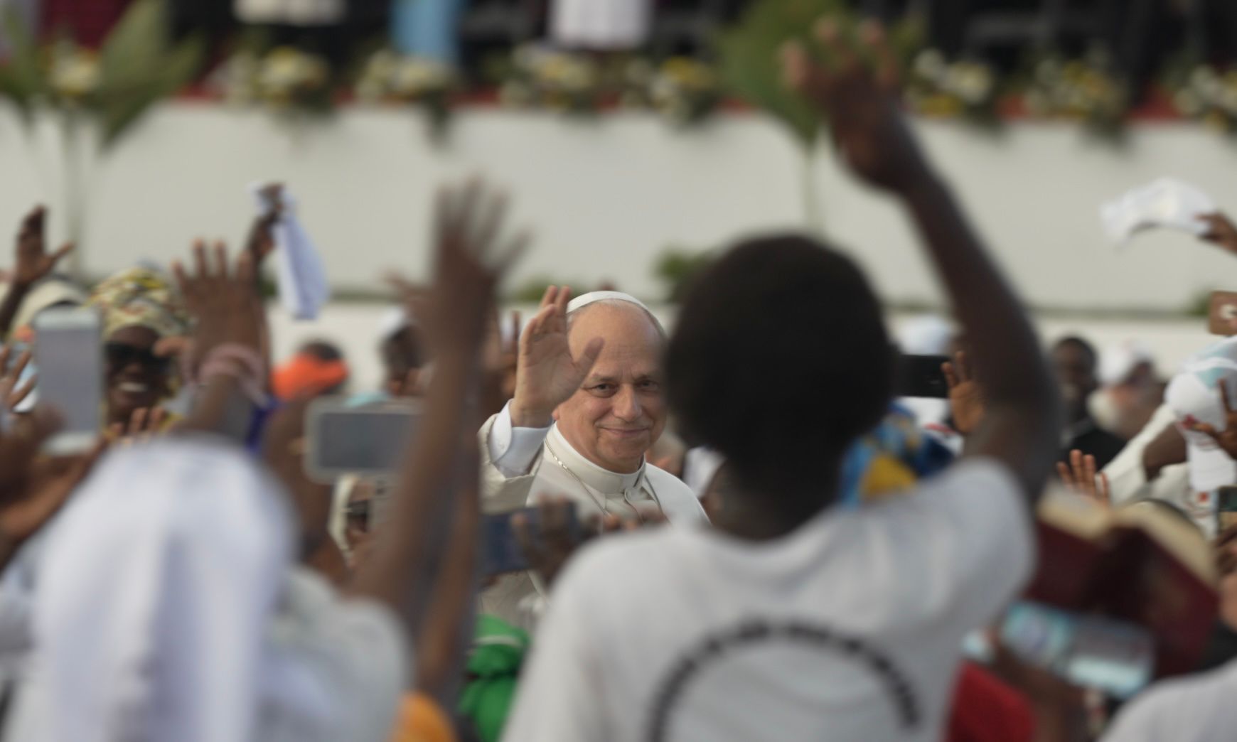 Pope Leo XIV urges Angola’s young people to build a world free of war, injustice, and poverty – #Catholic – KIMBAXE, Angola — Pope Leo XIV on Sunday urged young people in Angola to help build “a better, welcoming world, where there is no more war, injustice, poverty, or dishonesty,” during a rosary gathering at the Marian shrine of Mama Muxima.The shrine, whose name means “Mother of the Heart” in Kimbundu, is one of Angola’s best-known Marian sanctuaries. Built by the Portuguese in the 17th century on a hill overlooking the Kwanza River, it has long been a place of pilgrimage and prayer for Angolan Catholics.Addressing young people, members of the Legion of Mary, and other pilgrims gathered at the shrine, the pope said he was “pleased to share this moment of Marian prayer” with them.“Together we have recited the holy rosary, an ancient and simple devotion that originated in the Church as a form of prayer for everyone,” Leo said.Quoting St. John Paul II, the pope described the rosary as the prayer of a Christianity that has preserved the “freshness of its beginnings and feels drawn by the Spirit of God to ‘set out into the deep’ … to proclaim, and even cry out, before the world that Jesus Christ is Lord and Savior.”Leo said that in the “living and young Church of Angola,” one can “truly feel the freshness of faith and the power of the Spirit.”He reflected on the history of the shrine, saying it has been a place where “for centuries, many men and women have prayed in times of joy and also in moments of sorrow and great suffering in the history of this country.”“For a long time now, Mama Muxima has quietly worked to keep the heart of the Church alive and beating,” he said. “Her heart contains a multitude of hearts: yours, and those of many people who love, pray, celebrate, weep, and sometimes — even when unable to come in person — entrust their requests and petitions to letters and postal messages.”“Mama Muxima welcomes everyone, listens to everyone, and prays for everyone,” he added.Meditating on the glorious mysteries, the pope said the faithful were contemplating both their destiny in Christ and their mission in his love.“At Easter, Christ conquered death, showing us the way back to the Father,” Leo said. “And so that we too may walk this luminous and demanding path, sharing its beauty with the whole world, he has given us his Spirit, who animates and sustains us on our journey and in our mission.”“Like Mary, we too are made for heaven,” he continued. “As we journey toward heaven with joy, we look to her as our good Mother and model of holiness. Following her example, we bring the light of the risen One to the brothers and sisters we meet.”The pope also reflected on the popular title of the shrine, saying that although it is dedicated to the Immaculate Conception, the faithful have spontaneously renamed it the shrine of the “Mother of the Heart.”“It is a beautiful title, which makes us reflect on the heart of Mary: a pure and wise heart, capable of treasuring and pondering the extraordinary events in the life of the Son of God,” he said.Leo said praying the rosary means taking on a concrete responsibility toward others.“Praying the rosary, then, commits us to loving every person with a mother’s heart — concretely and generously — and to dedicating ourselves to the good of one another, especially the poorest,” he said.“A mother loves all her children in the same way and with her whole heart, even though each one is different,” the pope continued. “In the presence of the Mother of the Heart, we too want to promise to do likewise.”“We strive without measure so that no one may lack love,” he said. “We also seek to provide the necessities for living with dignity and happiness: that the hungry may have enough to eat, that the sick may receive the necessary care, that children may be guaranteed a proper education, and that the elderly may live their later years in peace.”“A mother thinks of all these things. Indeed, Mary thinks of all these things, and she also invites us to share in her maternal concern,” he added.Turning again to the young people gathered at the shrine, Leo pointed to the construction of a new sanctuary there as a sign of a larger calling.“Dear young people, members of the Legion of Mary, brothers and sisters, Our Lady asks us to let ourselves be moved by the sentiments of her heart, so that like her, we may be workers for justice and bearers of peace,” he said.“Here, a great project is underway: the construction of a new shrine, able to welcome all who come on pilgrimage. Everyone — especially you young people — should take this as a sign,” the pope said.“For the Mother of Heaven entrusts a great project to you as well: to build a better, welcoming world, where there is no more war, injustice, poverty or dishonesty, and where the principles of the Gospel increasingly inspire and shape hearts, structures, and programs, for the good of all.”“It is love that must triumph, not war!” Leo said. “This is what the heart of Mary — the heart of the Mother of all — teaches us.”“Let us set out, then, from this shrine as ‘messenger angels’ of life, bringing Mary’s tender embrace and God’s blessing to everyone,” he said.At the end of his address, the pope invoked a hymn familiar to devotees of Mama Muxima: “Mother of the Heart, we come to you to offer you everything.”“Dearest friends, let us offer everything to Mary, giving ourselves entirely to our brothers and sisters, and let us joyfully receive, through her intercession, the Lord’s blessing, so that we may bring it to everyone we meet,” he said. “Amen.”In his greeting, Bishop Emilio Sumbelelo of Viana highlighted the importance of devotion to Mama Muxima in Angola and noted that in 2022 the cornerstone of a future basilica was laid by the president of the republic and blessed by the late Cardinal Alexandre do Nascimento. The basilica will be dedicated to Our Lady of the Conception of Muxima, fulfilling a promise made by the Angolan government to the Catholic Church during St. John Paul II’s 1992 visit to the country.For many Angolans, the shrine remains a powerful symbol of faith, national memory, and hope.This story was first published by ACI Stampa, the Italian-language sister service of EWTN News. It has been translated and adapted by EWTN News English.