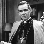 Beatification candidate Fulton Sheen forged strong ties in Paterson #Catholic - Sometime in 1974, Lo Anne Mayer, formerly of Corpus Christi Parish in Chatham Township, N.J., received a surprise phone call. On the other end was Archbishop Fulton J. Sheen, the world-renowned Catholic radio and TV evangelist. They met briefly after a talk he gave at another parish in the Paterson Diocese, N.J., and here he was asking her, “What do you think about St. Joseph?” — the topic of an upcoming presentation.
“I realized that Archbishop Sheen called people to get their views on particular topics — the Blessed Mother or St. Joseph — to make his talks more relevant to his audience. I was impressed; I didn’t know any priest who did that,” said Mayer, who first heard him speak at Christ the King Church in the New Vernon neighborhood of Harding Township, N.J., in 1974. “I saw Christ in Archbishop Sheen. His total dedication to the Lord was part of his persona. I felt as if I were in the presence of a saint,” she said.
So it was no surprise when Mayer, 85, now living in Manchester, N.J., heard the news on March 25 that Archbishop Sheen — now Venerable Fulton J. Sheen — is getting a step closer to sainthood. With joy, she plans to attend with her family the Mass of his beatification, where he will be designated as “blessed.” This will take place on Thursday, Sept. 24, at The Dome at America’s Center in St. Louis, Mo.
That first conversation in 1974 blossomed into a close family friendship. Venerable Sheen often spoke with Mayer at length on the phone and visited their home for dinner. Through Mayer, he became reacquainted with the Discalced Carmelites of the Most Blessed Virgin Mary of Mount Carmel in Morristown, N.J. He also baptized her and her husband Raymond’s youngest child, Michael, at Corpus Christi in 1975.
“I couldn’t be happier about Archbishop Sheen’s beatification,” said Mayer, who had started helping promote his cause before his home diocese in Peoria, Ill., opened it in 2002. “I know Archbishop Sheen would not have wanted this [beatification], but he needs to be recognized. People around the globe know him for his powerful preaching and are still interested in him,” she said.
Mayer will discuss Venerable Sheen and his beatification this Friday, May 8, his birthday, while recording an episode of the Beyond the Beacon podcast with Bishop Kevin J. Sweeney and Communications Director Jai Agnish. The episode will be available on all major podcast platforms on March 14, 2026.
Venerable Sheen earned worldwide renown as one of the 20th century’s leading English-speaking Catholic preachers. He used books, radio, and TV to reach a broad audience. Decades later, his program, “Life Is Worth Living,” resonates with younger Catholics through EWTN reruns. In 1979, Sheen died in New York at age 84.
“Archbishop Sheen was down to earth, speaking simply from the heart for everybody to understand,” said Mayer. She recalled how he spoke to her children before dinner, mesmerizing them with his message and presence. “As a young mother, Archbishop Sheen helped my faith. He was understanding and kind,” she said.
In 2012, Pope Benedict XVI declared Archbishop Sheen “venerable” for his heroic virtue. In 2019, Pope Francis recognized a miracle attributed to Sheen, paving the way for beatification. The Vatican, however, paused the process to investigate — and ultimately cleared him of — allegations from Sheen’s tenure as bishop of Rochester, N.Y. Mayer remains optimistic that a second miracle will be recognized to advance him to sainthood.
In 1984, Mayer participated in the first national gathering of the Archbishop Fulton J. Sheen Foundation at the Madison Hotel in Madison, N.J. She later chaired the organization and now serves on its advisory board. Mayer traveled to Peoria to witness the sealing of roughly 500 pages of documents for the cause for review in Rome.
Over the years, Mayer heard Venerable Sheen speak at other local parishes. She also invited him to the Carmelite monastery in Morristown, where he delivered the homily at the dedication Mass of the chapel in 1941. He quickly became friends with the community and made subsequent visits. “He made the Carmelites happy,” Mayer said.
Previously, Venerable Sheen had another diocesan connection: Yolanda Holliger of Immaculate Heart of Mary Parish in Wayne, N.J. He married her to his cousin, Tom, baptized their six children, and remained close to their family. Both Holligers testified in his cause and have since died.
“Archbishop Sheen had a saintly aura,” Holliger told The Beacon in a 2008 interview. “With him, you felt you were in heaven — perfect happiness.”
Mayer encourages local faithful to watch Venerable Sheen’s beatification Mass on EWTN on Sept. 24, starting at 3 p.m. EST.