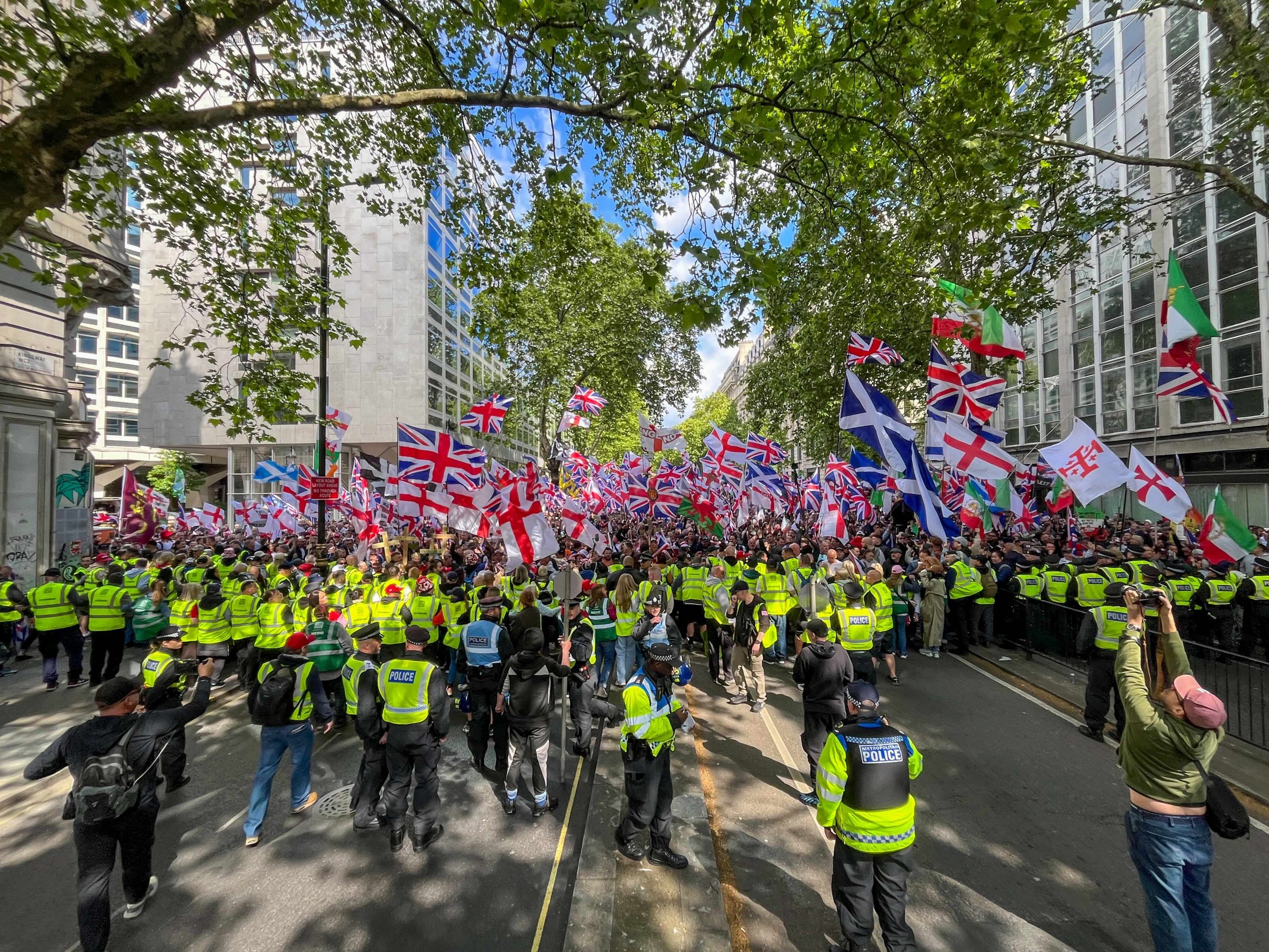 Christian faith looms large at ‘Unite The Kingdom’ protest in London – #Catholic – This weekend, tens of thousands of protesters gathered under an overcast sky in central London for a rally led by political activist and recent Christian convert, Tommy Robinson.Under Union flags and banners of ‘Make England Great Again’, protesters chanted anti-government slogans such as “We want Starmer out.” Many attendees said they felt white working-class Britons are being marginalized and Christian values eroded.Robinson – whose real name is Stephen Yaxley-Lennon – converted to Christianity while in prison in 2025, serving a sentence for contempt of court. Christianity has become an increasingly visible theme at these gatherings, with Robinson posting the Lord’s Prayer on X before the event.“British patriots need to realize that if they want the country to be great again, they need to go back to our Christian heritage,” Luke Barker from The Lord’s Work Trust said, as he handed out leaflets to the passing crowd titled ‘Common Sense: What the Bible has to say on the issue of immigration’. “We’re to welcome the stranger … but there are rules that come with that”, he maintains.At just 17, ‘Young Bob’, whose real name is Gregory Moffitt, has 140k followers tuning into his controversial political debates on X. Asked whether he thought the protest was in line with Jesus’ message of welcoming the stranger and loving your neighbour, he told me: “St. Thomas Aquinas talks about the economic procession of love, and he gives the example, where you obviously express more love to your mother than you would a foreigner … just because I love my neighbour doesnʼt mean they have to live in my house”.Along with many of his followers, Robinson frequently criticizes Islam. “They say theyʼre a religion of peace and love,” protester Kenny Moffett said, “but you see what goes on in those countries. People are being beheaded, women being stoned to death, women being made to cover up and never to be seen again.”London’s Metropolitan Police deployed over 4,000 officers to police three major events that coincided in the capital. By early Saturday evening, the force had confirmed 43 arrests, including at the Unite The Kingdom protest and a Palestinian demonstration taking place nearby.Some 11 foreign “far-right agitators” were blocked from entering the country to attend the event according to the Home Office, including American influencer Valentina Gomez.Prime Minister Sir Keir Starmer responded to the protests saying: “Weʼre in a fight for the soul of this country, and the Unite the Kingdom march this weekend is a stark reminder of exactly what we are up against."“Its organizers are peddling hatred and division, plain and simple. We will block those coming into the UK who seek to incite hatred and violence.”Asked why he thought Christianity had become such a big focus of the protests, Rev. Chris Wickland said: “Many people are beginning to realize that their heritage, and the way of life they like, comes from Christianity. And they realize that if they donʼt defend Christianity, the way of life they know is gone”.
 
 Christianity has become an increasingly visible theme at these gatherings, with Robinson posting the Lord’s Prayer on X before the event. | Credit: Elliot Hartley
 
 “My grandad was a vicar in the Church of England, and his influence pushed me in that direction,” Nathan Marwwod said while carrying a wooden cross over his shoulder. “It’s the original reason that England succeeded. It was built on Christian values, and all the other things have come with it.”“They are the values that create the most prosperous and innovative societies, and the most vibrant and rejuvenating societies,” Kieran Reid added. “The best places historically are the ones of Christian origin.”