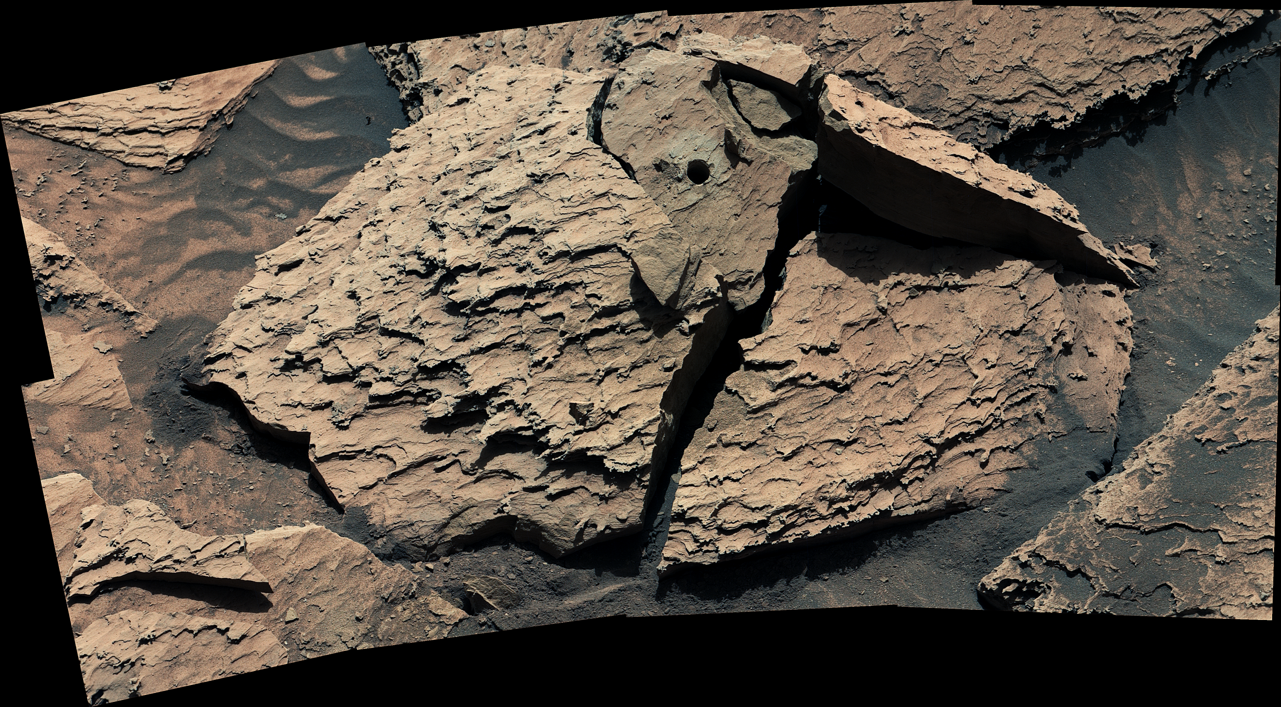 Curiosity Shakes Loose a Pesky Rock – NASA’s Curiosity Mars rover used its Mast Camera, or Mastcam, to capture this view of a rock nicknamed “Atacama” on May 6, 2026, the 4,877th Martian day, or sol, of the mission. The rock had gotten stuck to the drill on the end of Curiosity’s robotic arm on April 25.