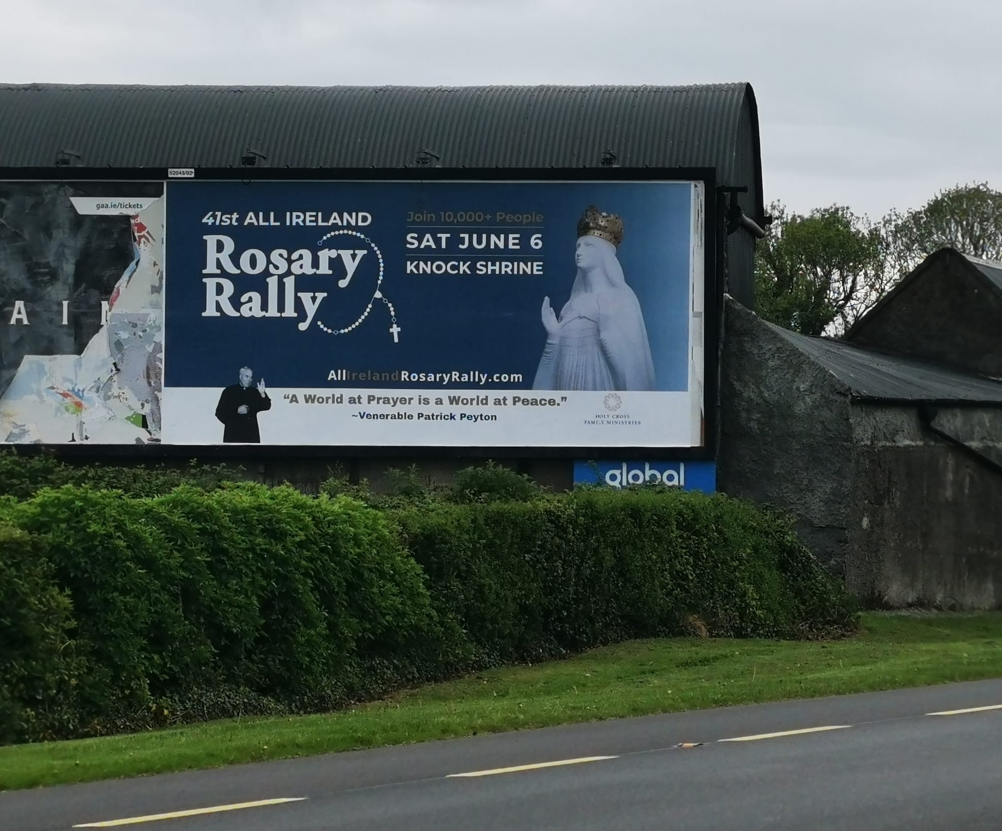 Nationwide billboard campaign in Ireland invites thousands to rosary rally – #Catholic – The All Ireland Rosary Rally scheduled for June 6 in Knock will be the largest Catholic event in Ireland this year, and organizers have adopted an uncommon promotional tactic to catch the attention of the faithful — a countrywide billboard campaign.Building on last year’s turnout when more than 10,000 people gathered for the 40th Rosary Rally in Knock, famous for its shrine and as a pilgrimage destination, rally organizers hope the two-week campaign will attract an even bigger audience. It is the first time the event has been advertised using billboards. Fifty sites throughout Ireland were chosen, including a number in Northern Ireland.
 
 A billboard posted in a parking lot in Derry City in Ireland advertises the upcoming All Ireland Rosary Rally on June 6, 2026. | Credit: Photo courtesy of the All Ireland Rosary Rally
 
 “We chose billboards because Father Patrick Peyton was famous for his billboards in running his rosary rallies around the world, some of which attracted crowds of 2 million people,” Father Marius O’Reilly, one of the rally organizers, told EWTN News.The billboards have attracted reaction and comments online and in the mainstream media. The Irish News, a daily newspaper published in Belfast, reported that Archbishop Eamon Martin and Bishop Donal McKeown plan to “reconsecrate Ireland to the Immaculate Heart of Mary at the event, which organizers describe as a national moment of prayer for peace.”Parishes have been drawing people’s attention to the billboard campaign as well. Holy Family Parish in Drogheda spotted one of the billboards in the town and posted on its Facebook page: “A giant reminder on the Dublin Road in Drogheda from the All Ireland Rosary Rally. Book your spot on our bus to Knock.”
 
 A billboard along the road in Drogheda, an industrial and port town in County Louth on the east coast of Ireland, 27 miles north of Dublin, advertises the upcoming All Ireland Rosary Rally on June 6, 2026. | Credit: Photo courtesy of the All Ireland Rosary Rally
 
 O’Reilly explained to EWTN News that the cost of the billboards has been borne by sponsors and voluntary donations. “Sponsors are paying for the posters and indeed, this huge event is possible because of the generosity of so many. People are not charged on the day; thereʼs no ticket price. So the event relies heavily on the generosity and support of many people across Ireland and beyond. People are responding very positively, and with great enthusiasm.”The goal of the rally’s organizing committee was a billboard presence in as many counties and population centers as possible. “We tried to ensure that every county would be represented with the billboards, and more so in the cities,” O’Reilly said. “I think it is encouraging people in their faith and itʼs just part of the renewal in Ireland thatʼs taking place. The Irish have a great love for Our Lady in the rosary.”
 
 A billboard advertising the All Ireland Rosary Rally on June 6, 2026, is spotted in Callan, County Kilkenny. Fifty sites throughout Ireland were chosen for the billboards, including a number in Northern Ireland. | Credit: Photo courtesy of the All Ireland Rosary Rally
 
 He continued: “The devotion to Our Lady is evident on the highways and byways of our country; we have huge grottos everywhere around Ireland, so Our Lady is very, very important to the Irish. Now for the duration of the campaign, people of all faiths and none can see Our Lady on a billboard, as well as the grottos, inviting them to come to Knock to pray for peace in our world and for the renewal of our faith in Ireland.”Partners for this yearʼs rally include the Father Peyton Centre in Attymass, County Mayo, and Holy Cross Family Ministries, which both continue the work of Peyton. International speakers include Father Chris Alar, Nikki Kingsley, and Bishop Oliver Doeme.Over 10,000 pilgrims are expected to attend this year, with 50 buses already booked to bring people to the Knock shrine.