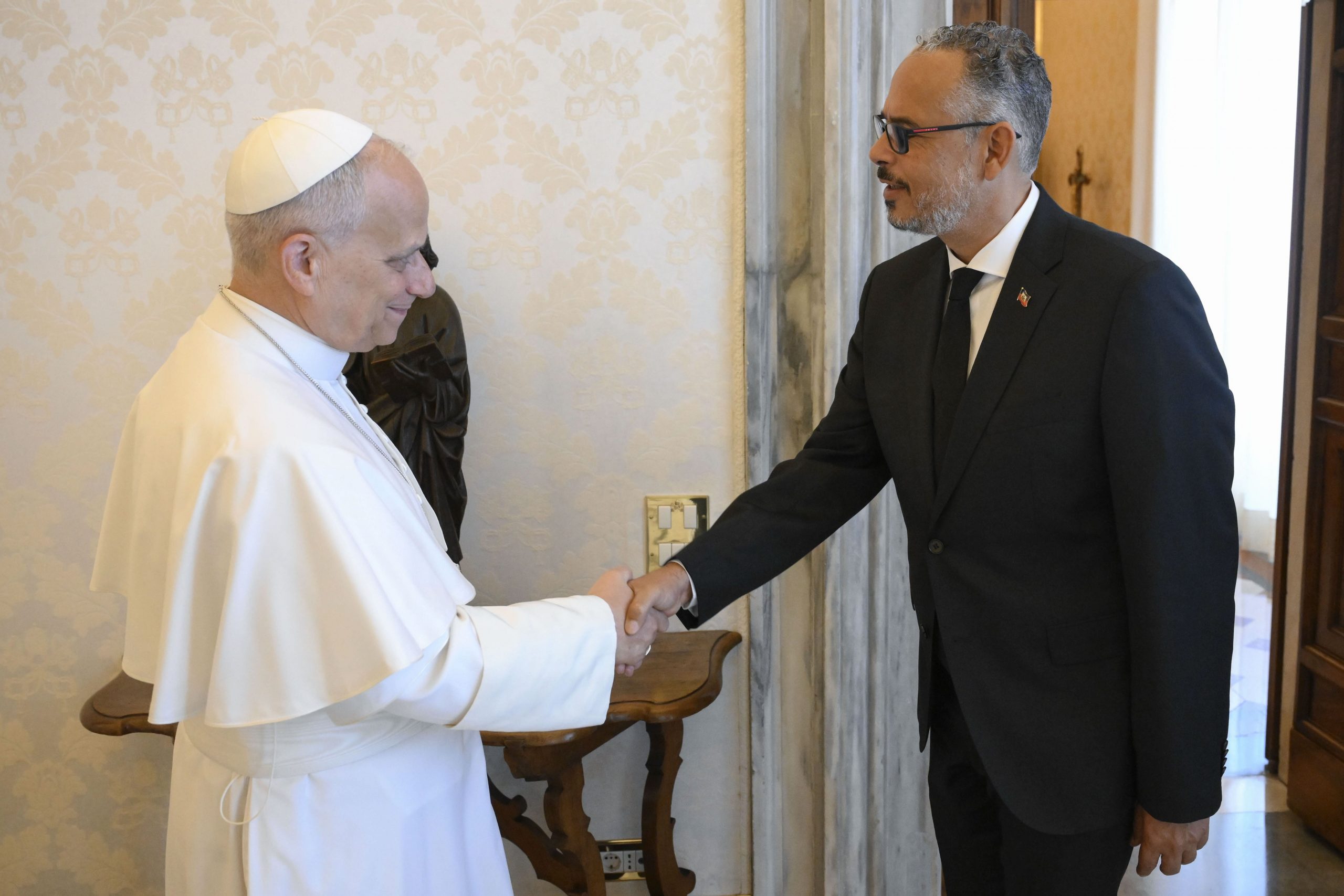 Pope Leo meets with Haiti’s prime minister – #Catholic – Alix Didier Fils-Aimé, prime minister of Haiti, a country which continues to suffer from a wave of violence and insecurity, was received by Pope Leo on Saturday.Following the meeting, the Holy See Press Office reported that the discussions between the two men focused on “the good relations between the Holy See and Haiti” and “the valuable contribution that the Church offers to the country at this particular time.”The meeting’s readout indicated that various current issues facing Haiti were also addressed during the meeting, including “the socio-political situation and challenges in the humanitarian matters, migration, and security” as well as “the necessary contribution of the international community in addressing the present difficulties.”Following his meeting with the Holy Father, the prime minister was received by Cardinal Pietro Parolin, the Vatican Secretary of State, and Archbishop Paul Richard Gallagher, Secretary for Relations with States and International Organizations.Haiti’s ongoing turmoilHaiti continues to experience a complex situation of violence and insecurity, particularly in the country’s capital of Port-au-Prince, where armed gangs operate freely, controlling a large portion of the region.In the midst of this backdrop, which also affects the Catholic Church, general elections are slated to be held on August 30, 2026, to elect the new president, members of the Senate and the Chamber of Deputies, as well as mayors.The last elections in Haiti took place in 2016 and were marked by controversy. Following that process, Jovenel Moïse assumed the presidency. Moïse was assassinated in 2021 and since then Haiti has spiraled into further political chaos and violence.Given the situation, in February of this year Bishop Pierre-André Dumas of Anse-à-Veau-Miragoâne, the current vice president of the country’s bishops’ conference, anticipated that this year’s elections will neither be “transparent” nor “democratic.”