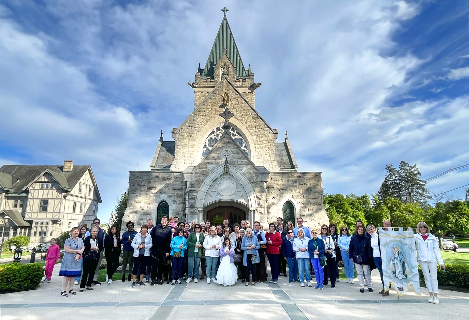 Rosary procession in Madison reflects community’s deep faith #Catholic – On May 11, parishioners gathered at St. Vincent Martyr Church in Madison in honor of the Month of Mary for the Rosary Altar Society’s Rosary Procession, reflecting the faith and devotion of the community’s faithful.
The procession began at St. Vincent Church with First Communicants crowning the statue of the Blessed Mother, then processed along the streets of Madison as members of the community stopped to watch.
Led by a banner of the Blessed Mother, the procession included Father Owen B. Moran, pastor of St. Vincent’s, Father Alex Nevitt, priest in residence, and Bishop (Bish), the parish’s “beloved Director of Tail Wagging.” Also in attendance were Sister of Charity Noreen Holly, principal of St. Vincent Martyr School, and Peter Solecki, director of music ministry.
Parishioners of all ages took part in the procession, while those unable to walk gathered prayerfully inside the church. Following the procession, the community returned to St. Vincent Martyr for fellowship.


Click here to subscribe to our weekly newsletter.