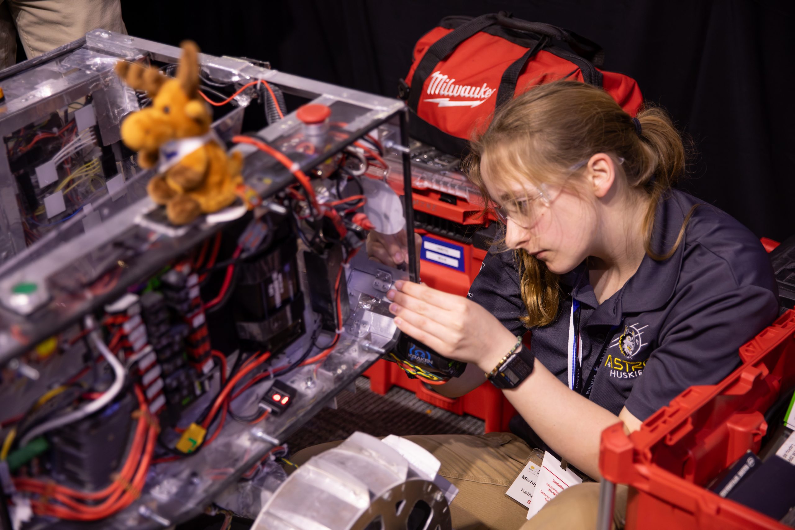 Students Build Moon Robots for NASA’s 2026 Lunabotics Challenge – Katherine Rauscher, of Michigan Technological University, prepares her team’s prototype lunar robot for its turn during the finals for NASA’s 2026 Lunabotics Challenge competition on Tuesday, May 19, 2026, inside the Astronauts Memorial Foundation’s Center for Space Education at the Kennedy Space Center Visitor Complex in Florida. Forty-seven teams from around the U.S. designed and built remote-controlled robots capable of traversing challenging lunar terrain while constructing regolith-based berm under conditions similar to those the agency will face as it returns to the lunar surface through Artemis.