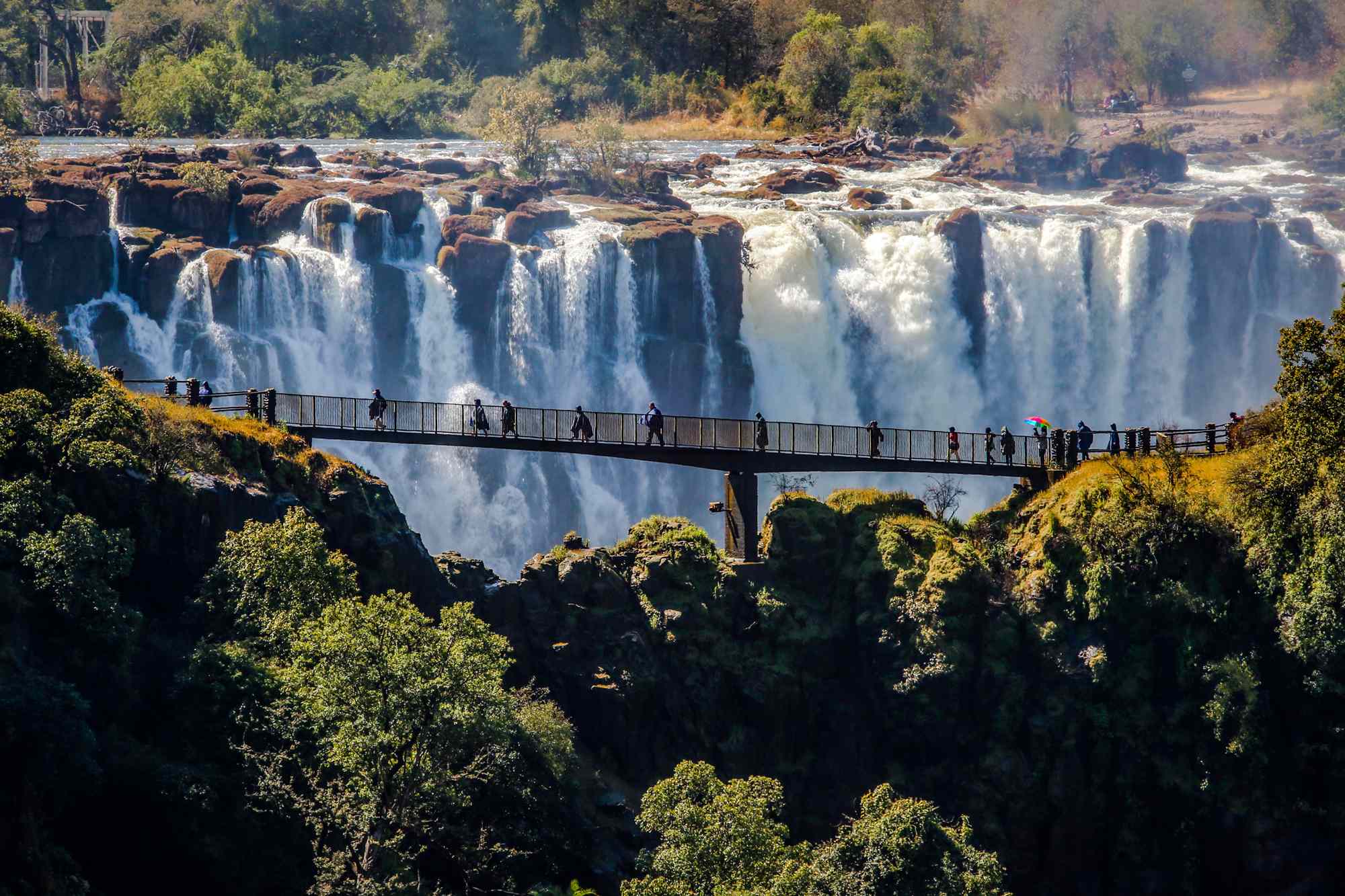 This Town Is a Gateway to the Largest Waterfall in the World—With Easy National Park Access, Safaris, and Stunning Views #Travel Staying here gets you easy access to one of the seven natural wonders of the world. This Town Is a Gateway to the Largest Waterfall in the World—With Easy National Park Access, Safaris, and Stunning Views #Travel Staying here gets you easy access to one of the seven natural wonders of the world.