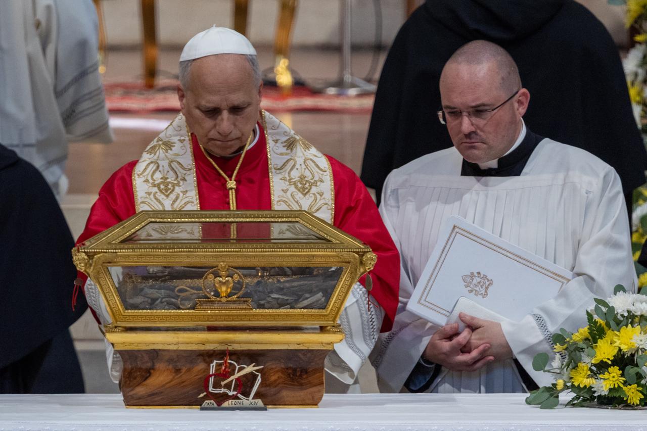 At St. Augustine’s tomb, Pope Leo XIV urges Pavia to honor every human life – #Catholic – PAVIA, Italy — Pope Leo XIV on Saturday visited the Basilica of St. Peter in Ciel d’Oro in Pavia, where the relics of St. Augustine are kept, in what amounted to a kind of homecoming for the Augustinian pope.The basilica, whose construction began in the eighth century, has housed the mortal remains of St. Augustine since around the year 722, when they arrived in Pavia from Cagliari. The relics had previously been brought to Sardinia from Hippo in 504.The June 20 stop continued Pope Leo’s Augustinian itinerary. In April, during his apostolic journey to Algeria, the pope visited Annaba, the ancient Hippo, where Augustine served as bishop.Upon his arrival at the basilica, Pope Leo was welcomed by Father Joseph L. Farrell, prior general of the Order of St. Augustine; Father Gabriele Pedicino, provincial prior; and Father Gianfranco Casagrande, prior of the convent. The pope then met with the Augustinian community and, later in the cloister, with bishops of the Lombardy Episcopal Conference.The last papal visit to the Basilica of St. Peter in Ciel d’Oro took place in 2007, when Pope Benedict XVI came to Pavia and was welcomed by Father Robert Francis Prevost, then prior general of the Order of St. Augustine.Greeting those present in the cloister, where about 1,800 faithful were gathered inside and outside the basilica, Pope Leo spoke briefly off the cuff.“I know many of you,” he said. “St. Augustine teaches us to live and to love God and our brothers and sisters. Fraternal love and charity toward all are important; this is the message of Jesus and of St. Augustine. We are signs of love and charity, and we know how to live forgiveness, reconciliation, and peace.”In his greeting to the Augustinian community, Leo said that “St. Augustine is not ours; he belongs to the Church, and our mission is to make him known in the Church,” because Augustine “has so much to offer in this time.”The pope said it is necessary “to offer the message of love for Christ and love for the Church,” adding: “May St. Augustine always help us to live this mission.”In his address in the basilica, Pope Leo praised the Church in Pavia as “a community of ancient tradition that remains alive and present in the city and territory, attentive to the signs of this time and to its challenges, without allowing itself to be discouraged by fatigue, by the secularized context, and by the difficulties in transmitting the faith.”To avoid discouragement, he said, Christians need “a gaze animated by the spirit of faith” that helps them read reality more deeply and resist “a negative and pessimistic attitude, incapable of generating new life.”“The gaze that is required of us is instead that of Jesus,” he said.The pope asked what it means to be “a living Church,” answering that it requires remaining united to Christ, “the living stone, rejected by men but chosen by God.”“Christ is the foundation of the spiritual building,” Leo said. “He is the cornerstone placed as the basis of our ecclesial journey, of pastoral action, and of evangelization.”Being built in Christ, he said, protects the Church from the risk of becoming scattered or exhausted by “secondary things” that may be good but do not reach what is essential.“Since the center is Christ, we all draw from this one source and submit our efforts to the discernment that comes from his light and his word,” the pope said. “Then we help grow a Church in which people walk together, capable of renewing itself without division, in which all recognize one another as brothers and sisters and work joyfully in service of the kingdom of God.”Leo urged Christian communities to be centered on what is essential, “even if this should involve giving up some structures and some securities of the past.”“The essential thing is to live with Christ, and spreading his Gospel is what must be close to our hearts,” he said.The pope addressed that appeal first to priests, calling them to “always return to the center” and to unify everything in their relationship with the Lord. He also encouraged men and women religious, who he said often know the fatigue of updating the charism to which they belong, to begin again from Christ and share their gifts with the whole diocesan Church.In a secularized world, Leo said, Christians are called above all to bring “the joyful and liberating proclamation of Jesus Christ” and to help people discover or rediscover the faith.The pope then pointed again to Augustine, saying that “his thought, the story of his conversion, and his spirituality remind us of the value and primacy of interiority.”“As living stones, we are called to be a Church well rooted in the territory,” Pope Leo said, “a Church that walks amid the struggles and hopes of the people, expert in the art of listening and accompanying.”He emphasized the importance in Pavia of university pastoral ministry and dialogue with culture, saying that study and scientific work challenge believers to offer a faith capable of illuminating the human search for truth, justice, and beauty.Before the pope’s address, Bishop Corrado Sanguineti of Pavia described the local Church as “a Church on the journey,” marked by growing communion among religious communities, associations, movements, and pastoral efforts to reach people in the concrete circumstances of their lives.Farrell, the Augustinian prior general and Prevost’s successor, also addressed the pope. He said Pope Leo’s presence among the Augustinians had “inestimable meaning,” because they are “historically and spiritually, sons of the Church and sons of St. Augustine.”“We have St. Augustine for a father and the Church for a mother,” Farrell said, noting that the words would sound familiar to Leo because they were the same words then-Father Prevost had addressed to Pope Benedict XVI during his 2007 visit to Pavia.
Pope Leo XIV in Pavia, Italy, on June 20, 2026. | Credit: Daniel Ibáñez/EWTN News
After leaving the basilica, Pope Leo went to Piazza Duomo, where he prayed before the Blessed Sacrament and venerated the relics of St. Syrus, the first bishop of Pavia.On the steps of the cathedral, the pope blessed a heated cradle intended for abandoned newborns and prayed before the image of Our Lady of Colombina. The then-Cardinal Prevost had been expected to visit the shrine of Colombina last year, but his election to the papacy made the visit impossible.Speaking off the cuff on the cathedral steps, Pope Leo greeted young people and the large Peruvian community present in the city.“We all want to live in peace,” he said. “It is very important that we never lose hope. But, as St. Augustine told us, if we want to change the times, if we want the world to live in peace, we must begin with ourselves.”“That means no more words of hatred, no more insults, no more bullying, no more all those things that create war between people, between communities, between countries,” the pope said. “We must all learn to be builders of peace and promoters of reconciliation.”After the visit to the cathedral, Pope Leo walked despite the intense heat to Piazza Vittoria for a meeting with the city’s residents.The beauty of Pavia, Leo said, is demanding because it represents “the precious inheritance of a past that becomes a commitment for the present.”“The city is in fact a gift and a task for those who live there,” he said.Referring to schools, universities, hospitals, and parishes, the pope said they are “significant places” that testify to welcome, education, and culture. In different ways, he said, they attest to “the same care for the person-in-community, with his dignity and his values,” which unite citizens as one people and also underlie the Italian Constitution.The city, Pope Leo said, points to “a human condition: The city is one for all; it is singular and plural.”“To be social means to be solidary, behaving as authentic partners, motivated by the common good and not by partisan interests,” he said. “Citizens are always fellow citizens.”Speaking before about 3,500 people gathered between the cathedral and Piazza Vittoria, the pope warned against indifference and called for renewed participation in civic life.“When indifference seems to break apart our community, it is necessary to renew the active participation of all in city life,” he said. “Faced with forms of degradation and civic illiteracy, we are called to share languages of dedication and service, which safeguard squares, parks, and streets as places of encounter par excellence.”Good citizenship, he said, “knows how to cultivate concord through dialogue and constructive encounter among the people and cultures that animate Pavia.”“Today I invite each of you to repeat within yourselves: I care about our city,” the pope said. “I care about the health of the person next to me. I care about the beauty of the place where I live. I care about the quality of life in the environments where I work and where I spend my free time.”Leo also highlighted the University of Pavia, saying its students experience not “an agglomeration of knowledge” but a system capable of forming the person “without speculating on his labor.”“To promote the sciences, in fact, means to promote man, who must always remain the protagonist of his own research,” the pope said. “To every form of knowledge there corresponds a form of care.”Returning to Augustine, Leo said “one cannot believe without thinking, nor is it possible to illuminate the highest questions of reason without faith.”“With this trusting openness, human reason asks and plans,” he said. “It does not close itself within the logic of profit or domination but discovers new ways to care for itself and for the world.”Faith, he added, reminds people that they are not “subjects of an anonymous fate” but are sustained by the certainty that God is “creator and savior of life.”“Thanks to your commitment, Pavia is prosperous not only in goods but also in virtues: Always honor the dignity of every human life!” he said.Earlier in the day, Pope Leo began his brief but intense visit to Pavia at the National Center for Oncological Hadrontherapy, known by its Italian acronym CNAO.The papal helicopter landed in Pavia shortly before 2:40 p.m. on a day of particularly high temperatures. The pope was welcomed by local authorities and Sanguineti.“Great emotion, an atmosphere of joy, a hot day because of the heat — we think it is a beautiful moment for everyone and an experience of faith for many,” the bishop told accredited journalists gathered in the press room inside the bishop’s residence.The cancer center, inaugurated Feb. 15, 2010, treats patients with solid tumors that cannot be cured surgically or with traditional radiotherapy, using hadrontherapy: irradiation with beams of protons and carbon ions.CNAO was the first center dedicated to hadrontherapy in Italy and remains the only one in the country able to offer carbon ion therapy.Inside the facility, the pope greeted administrators, medical staff, and several children undergoing treatment at the center, together with their parents.“Help the whole world understand how, when there are difficult moments, if there is not the presence and love of the family, everything is more difficult,” the pope said off the cuff. “God does not want anyone to suffer. What God promises us is that he will always be present, even when we are too weak; he sends us angels.”The pope thanked CNAO, “which works miracles,” and its staff, saying “God works in our lives also through doctors, nurses, and so many people.”“When things are difficult,” he said, “let us place all our trust in God.”After leaving Pavia, Pope Leo was scheduled to stop in Sant’Angelo Lodigiano to venerate the relics of St. Frances Xavier Cabrini before returning to the Vatican.This story was first published in three parts by ACI Stampa, the Italian-language sister service of EWTN News. It has been translated and adapted by EWTN News English. At St. Augustine’s tomb, Pope Leo XIV urges Pavia to honor every human life – #Catholic – PAVIA, Italy — Pope Leo XIV on Saturday visited the Basilica of St. Peter in Ciel d’Oro in Pavia, where the relics of St. Augustine are kept, in what amounted to a kind of homecoming for the Augustinian pope.The basilica, whose construction began in the eighth century, has housed the mortal remains of St. Augustine since around the year 722, when they arrived in Pavia from Cagliari. The relics had previously been brought to Sardinia from Hippo in 504.The June 20 stop continued Pope Leo’s Augustinian itinerary. In April, during his apostolic journey to Algeria, the pope visited Annaba, the ancient Hippo, where Augustine served as bishop.Upon his arrival at the basilica, Pope Leo was welcomed by Father Joseph L. Farrell, prior general of the Order of St. Augustine; Father Gabriele Pedicino, provincial prior; and Father Gianfranco Casagrande, prior of the convent. The pope then met with the Augustinian community and, later in the cloister, with bishops of the Lombardy Episcopal Conference.The last papal visit to the Basilica of St. Peter in Ciel d’Oro took place in 2007, when Pope Benedict XVI came to Pavia and was welcomed by Father Robert Francis Prevost, then prior general of the Order of St. Augustine.Greeting those present in the cloister, where about 1,800 faithful were gathered inside and outside the basilica, Pope Leo spoke briefly off the cuff.“I know many of you,” he said. “St. Augustine teaches us to live and to love God and our brothers and sisters. Fraternal love and charity toward all are important; this is the message of Jesus and of St. Augustine. We are signs of love and charity, and we know how to live forgiveness, reconciliation, and peace.”In his greeting to the Augustinian community, Leo said that “St. Augustine is not ours; he belongs to the Church, and our mission is to make him known in the Church,” because Augustine “has so much to offer in this time.”The pope said it is necessary “to offer the message of love for Christ and love for the Church,” adding: “May St. Augustine always help us to live this mission.”In his address in the basilica, Pope Leo praised the Church in Pavia as “a community of ancient tradition that remains alive and present in the city and territory, attentive to the signs of this time and to its challenges, without allowing itself to be discouraged by fatigue, by the secularized context, and by the difficulties in transmitting the faith.”To avoid discouragement, he said, Christians need “a gaze animated by the spirit of faith” that helps them read reality more deeply and resist “a negative and pessimistic attitude, incapable of generating new life.”“The gaze that is required of us is instead that of Jesus,” he said.The pope asked what it means to be “a living Church,” answering that it requires remaining united to Christ, “the living stone, rejected by men but chosen by God.”“Christ is the foundation of the spiritual building,” Leo said. “He is the cornerstone placed as the basis of our ecclesial journey, of pastoral action, and of evangelization.”Being built in Christ, he said, protects the Church from the risk of becoming scattered or exhausted by “secondary things” that may be good but do not reach what is essential.“Since the center is Christ, we all draw from this one source and submit our efforts to the discernment that comes from his light and his word,” the pope said. “Then we help grow a Church in which people walk together, capable of renewing itself without division, in which all recognize one another as brothers and sisters and work joyfully in service of the kingdom of God.”Leo urged Christian communities to be centered on what is essential, “even if this should involve giving up some structures and some securities of the past.”“The essential thing is to live with Christ, and spreading his Gospel is what must be close to our hearts,” he said.The pope addressed that appeal first to priests, calling them to “always return to the center” and to unify everything in their relationship with the Lord. He also encouraged men and women religious, who he said often know the fatigue of updating the charism to which they belong, to begin again from Christ and share their gifts with the whole diocesan Church.In a secularized world, Leo said, Christians are called above all to bring “the joyful and liberating proclamation of Jesus Christ” and to help people discover or rediscover the faith.The pope then pointed again to Augustine, saying that “his thought, the story of his conversion, and his spirituality remind us of the value and primacy of interiority.”“As living stones, we are called to be a Church well rooted in the territory,” Pope Leo said, “a Church that walks amid the struggles and hopes of the people, expert in the art of listening and accompanying.”He emphasized the importance in Pavia of university pastoral ministry and dialogue with culture, saying that study and scientific work challenge believers to offer a faith capable of illuminating the human search for truth, justice, and beauty.Before the pope’s address, Bishop Corrado Sanguineti of Pavia described the local Church as “a Church on the journey,” marked by growing communion among religious communities, associations, movements, and pastoral efforts to reach people in the concrete circumstances of their lives.Farrell, the Augustinian prior general and Prevost’s successor, also addressed the pope. He said Pope Leo’s presence among the Augustinians had “inestimable meaning,” because they are “historically and spiritually, sons of the Church and sons of St. Augustine.”“We have St. Augustine for a father and the Church for a mother,” Farrell said, noting that the words would sound familiar to Leo because they were the same words then-Father Prevost had addressed to Pope Benedict XVI during his 2007 visit to Pavia.
Pope Leo XIV in Pavia, Italy, on June 20, 2026. | Credit: Daniel Ibáñez/EWTN News
After leaving the basilica, Pope Leo went to Piazza Duomo, where he prayed before the Blessed Sacrament and venerated the relics of St. Syrus, the first bishop of Pavia.On the steps of the cathedral, the pope blessed a heated cradle intended for abandoned newborns and prayed before the image of Our Lady of Colombina. The then-Cardinal Prevost had been expected to visit the shrine of Colombina last year, but his election to the papacy made the visit impossible.Speaking off the cuff on the cathedral steps, Pope Leo greeted young people and the large Peruvian community present in the city.“We all want to live in peace,” he said. “It is very important that we never lose hope. But, as St. Augustine told us, if we want to change the times, if we want the world to live in peace, we must begin with ourselves.”“That means no more words of hatred, no more insults, no more bullying, no more all those things that create war between people, between communities, between countries,” the pope said. “We must all learn to be builders of peace and promoters of reconciliation.”After the visit to the cathedral, Pope Leo walked despite the intense heat to Piazza Vittoria for a meeting with the city’s residents.The beauty of Pavia, Leo said, is demanding because it represents “the precious inheritance of a past that becomes a commitment for the present.”“The city is in fact a gift and a task for those who live there,” he said.Referring to schools, universities, hospitals, and parishes, the pope said they are “significant places” that testify to welcome, education, and culture. In different ways, he said, they attest to “the same care for the person-in-community, with his dignity and his values,” which unite citizens as one people and also underlie the Italian Constitution.The city, Pope Leo said, points to “a human condition: The city is one for all; it is singular and plural.”“To be social means to be solidary, behaving as authentic partners, motivated by the common good and not by partisan interests,” he said. “Citizens are always fellow citizens.”Speaking before about 3,500 people gathered between the cathedral and Piazza Vittoria, the pope warned against indifference and called for renewed participation in civic life.“When indifference seems to break apart our community, it is necessary to renew the active participation of all in city life,” he said. “Faced with forms of degradation and civic illiteracy, we are called to share languages of dedication and service, which safeguard squares, parks, and streets as places of encounter par excellence.”Good citizenship, he said, “knows how to cultivate concord through dialogue and constructive encounter among the people and cultures that animate Pavia.”“Today I invite each of you to repeat within yourselves: I care about our city,” the pope said. “I care about the health of the person next to me. I care about the beauty of the place where I live. I care about the quality of life in the environments where I work and where I spend my free time.”Leo also highlighted the University of Pavia, saying its students experience not “an agglomeration of knowledge” but a system capable of forming the person “without speculating on his labor.”“To promote the sciences, in fact, means to promote man, who must always remain the protagonist of his own research,” the pope said. “To every form of knowledge there corresponds a form of care.”Returning to Augustine, Leo said “one cannot believe without thinking, nor is it possible to illuminate the highest questions of reason without faith.”“With this trusting openness, human reason asks and plans,” he said. “It does not close itself within the logic of profit or domination but discovers new ways to care for itself and for the world.”Faith, he added, reminds people that they are not “subjects of an anonymous fate” but are sustained by the certainty that God is “creator and savior of life.”“Thanks to your commitment, Pavia is prosperous not only in goods but also in virtues: Always honor the dignity of every human life!” he said.Earlier in the day, Pope Leo began his brief but intense visit to Pavia at the National Center for Oncological Hadrontherapy, known by its Italian acronym CNAO.The papal helicopter landed in Pavia shortly before 2:40 p.m. on a day of particularly high temperatures. The pope was welcomed by local authorities and Sanguineti.“Great emotion, an atmosphere of joy, a hot day because of the heat — we think it is a beautiful moment for everyone and an experience of faith for many,” the bishop told accredited journalists gathered in the press room inside the bishop’s residence.The cancer center, inaugurated Feb. 15, 2010, treats patients with solid tumors that cannot be cured surgically or with traditional radiotherapy, using hadrontherapy: irradiation with beams of protons and carbon ions.CNAO was the first center dedicated to hadrontherapy in Italy and remains the only one in the country able to offer carbon ion therapy.Inside the facility, the pope greeted administrators, medical staff, and several children undergoing treatment at the center, together with their parents.“Help the whole world understand how, when there are difficult moments, if there is not the presence and love of the family, everything is more difficult,” the pope said off the cuff. “God does not want anyone to suffer. What God promises us is that he will always be present, even when we are too weak; he sends us angels.”The pope thanked CNAO, “which works miracles,” and its staff, saying “God works in our lives also through doctors, nurses, and so many people.”“When things are difficult,” he said, “let us place all our trust in God.”After leaving Pavia, Pope Leo was scheduled to stop in Sant’Angelo Lodigiano to venerate the relics of St. Frances Xavier Cabrini before returning to the Vatican.This story was first published in three parts by ACI Stampa, the Italian-language sister service of EWTN News. It has been translated and adapted by EWTN News English.