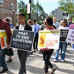 Catholics reaffirm human life’s value at Morristown procession, Mass #Catholic - Faithful of the Paterson Diocese, N.J., proclaimed in English and Spanish, “Jesus Protects and Saves the Unborn,” as they walked the streets of Morristown in prayer on June 6 during the Monthly Mass and Procession for Life with Bishop Kevin J. Sweeney at St. Margaret of Scotland Church, also in Morristown. Participants reasserted their commitment to the dignity of all human life, from birth to natural death.
Before the procession, Bishop Sweeney celebrated Mass at St. Margaret’s. Father Duberney Villamizar, pastor of St. Margaret’s, concelebrated, and Deacon Tim Holden of the parish assisted.
Afterward, Bishop Sweeney led the faithful in a rosary procession down Speedwell Avenue to Planned Parenthood, where they prayed in front of the facility for an end to abortion.
Many carried signs with pro-life messages in English and Spanish, such as “Jesus Protects and Saves the Unborn.” The marchers then returned to St. Margaret’s, where they prayed before the Blessed Sacrament.
Everyone is welcome to join the Mass and Procession for Life with Bishop Kevin J. Sweeney, which takes place on the first Saturday of each month at 8 a.m. at St. Margaret’s.
BEACON PHOTOS | JOE GIGLI
 [See image gallery at beaconnj.org] 

Click here to subscribe to our weekly newsletter.