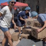 ‘Faith in action’: Over 5,000 volunteers in San Diego pack 2 million meals for those in need #Catholic – “Never did I ever think that it would be this big.”
Deacon Jim Scull was referring to the Million Meal Event, which he and a small team of deacons from the Diocese of San Diego launched five years ago. At the inaugural event, volunteers packed 1 million nutritious meals to distribute to impoverished families across the border in Tijuana and in Africa.
The deacons held the fifth edition of the Million Meal Event over the June 13-14 weekend, again returning to the expansive grounds of Cathedral Catholic High School. This year, around 5,100 volunteers doubled the number of meals they packed — to 2 million.
The event is a project of the diocese’s permanent deacons to serve the most vulnerable. They recruit volunteers at their parishes and raise funds to cover the event’s costs, which this year totaled about 0,000.
They collaborate with a Christ-centered nonprofit organization, Kids Around the World, which buys the bulk ingredients and distributes a portion of the meals overseas to the communities they serve. This year’s Million Meal Event was the largest of the nearly 200 packing events the agency will support in 2026, said its CEO, Jeff Rosene.
Click here to subscribe to our weekly newsletter.
Two years ago, the deacons joined forces with Catholic Charities, also part of the Diocese of San Diego, to strengthen their event.
Catholic Charities works with many parishes to serve needy families in their communities through its Emergency Food Distribution Network+. Under the leadership of San Diego’s Bishop Michael M. Pham, Catholic Charities set out to pack an additional 1 million meals this year to provide for hungry families across the diocese, which runs the length of California’s border with Mexico.
Of the remaining million meals, 500,000 meals will again be destined for an urban center that serves needy families in Tijuana, Casa de los Pobres, operated by Franciscan sisters. And the other 500,000 meals will be transported to Ecuador, where Kids Around the World serves 4,000 poor children in its feeding and discipleship program.
“You are not only packing meals today but you’re also feeding people in both San Diego and Imperial counties,” Catholic Charities’ CEO, Appaswamy “Vino” Pajanor, told the volunteers during the morning shift June 13.
“Who is my neighbor?” Pajanor asked them. “It’s my neighbor next door as well as my neighbor who I don’t know.”
The volunteers — about 34% more than last year — came from 78 of the diocese’s parishes and from schools and other organizations. They cheerfully arrived in groups and families, some pushing strollers, as if they were going to an outdoor celebration. Participants ranged in age from around 8 to 80-plus.
They packed meals over two 2.5-hour shifts on Saturday and one on Sunday afternoon, working in assembly lines under large tents shading them from the hot sun. Many volunteers worked alongside people they knew, while others quickly introduced themselves and got to work.
They measured ingredients that went into each packet — red lentils, dehydrated vegetables, vitamins and minerals — and to seal and label each one. Then they placed the packets in boxes, which in turn were stacked for easy transportation.
A DJ played popular tunes during the packing shifts, with volunteers dancing along. Periodically, a deacon or another organizer would announce a new milestone — “We just packed another 200,000 meals!” — to widespread cheering.
Many volunteers were veterans of the event, while others were newcomers.
“It’s an amazing day for the community,” said Nicole Winfield, from St. James Academy, as she worked at a table alongside her children. “My kids enjoy it every year. It kicks off their summertime. To do something for others is our faith in action,” she told The Southern Cross, San Diego’s diocesan news outlet.
This was the first time for Briana Powell, a young adult member of The Immaculata Parish. She was part of a group of about 50 volunteers from the parish who turned out for the Saturday morning shift, all sporting bright blue T-shirts.
She said she learned about the event one Sunday after Mass, when she stopped by a booth, and signed up on the spot.
“I wanted to give back to the community,” said Powell. “And to be a part of something great.”
Catholic Charities’ CEO, Pajanor, said he was sharing the Million Meal Event with the other Catholic Charities agencies across the country to show the impact the project can have in parishes, the diocese’s home region and globally.
At the packing tables, the deacons and priests worked alongside their parishioners. Newly ordained Deacon Joseph Parker, from Resurrection Parish in Escondido, was one of them.
“Today we’re helping to feed those who are in most need,” the deacon said. “We’re here to be able to serve. This is the body of Christ. We’re all called to serve any way we can.”
Between shifts on Saturday, Jesuit Father Eduardo Samaniego, who directs the diocese’s Office for the Permanent Diaconate, reflected on the challenges of starting and growing the event during its five-year existence.
By 2024, volunteer interest had been so high that the deacons set out to pack 1.5 million meals, but accomplishing that goal turned out harder than expected. Last year they reverted to the original 1 million meal goal.
“Who would have thought we would get it up to 2 million?” he asked.
He noted the number of children and young people who participated in the event.
“The kids grow up enjoying it,” he said. “And eventually, you teach them why we do it.”
He pointed to a large banner that greeted volunteers entering the school grounds on their way to the packing tables, bearing the Gospel passage in Matthew 25: “For I was hungry and you gave me food.”
“We’re doing this for Jesus,” he said.
Aida Bustos, director of media for the San Diego Diocese, is editor of The Southern Cross, the diocesan news outlet. This article was published in The Southern Cross and distributed in partnership with OSV News.
‘Faith in action’: Over 5,000 volunteers in San Diego pack 2 million meals for those in need #Catholic – “Never did I ever think that it would be this big.”
Deacon Jim Scull was referring to the Million Meal Event, which he and a small team of deacons from the Diocese of San Diego launched five years ago. At the inaugural event, volunteers packed 1 million nutritious meals to distribute to impoverished families across the border in Tijuana and in Africa.
The deacons held the fifth edition of the Million Meal Event over the June 13-14 weekend, again returning to the expansive grounds of Cathedral Catholic High School. This year, around 5,100 volunteers doubled the number of meals they packed — to 2 million.
The event is a project of the diocese’s permanent deacons to serve the most vulnerable. They recruit volunteers at their parishes and raise funds to cover the event’s costs, which this year totaled about 0,000.
They collaborate with a Christ-centered nonprofit organization, Kids Around the World, which buys the bulk ingredients and distributes a portion of the meals overseas to the communities they serve. This year’s Million Meal Event was the largest of the nearly 200 packing events the agency will support in 2026, said its CEO, Jeff Rosene.
Click here to subscribe to our weekly newsletter.
Two years ago, the deacons joined forces with Catholic Charities, also part of the Diocese of San Diego, to strengthen their event.
Catholic Charities works with many parishes to serve needy families in their communities through its Emergency Food Distribution Network+. Under the leadership of San Diego’s Bishop Michael M. Pham, Catholic Charities set out to pack an additional 1 million meals this year to provide for hungry families across the diocese, which runs the length of California’s border with Mexico.
Of the remaining million meals, 500,000 meals will again be destined for an urban center that serves needy families in Tijuana, Casa de los Pobres, operated by Franciscan sisters. And the other 500,000 meals will be transported to Ecuador, where Kids Around the World serves 4,000 poor children in its feeding and discipleship program.
“You are not only packing meals today but you’re also feeding people in both San Diego and Imperial counties,” Catholic Charities’ CEO, Appaswamy “Vino” Pajanor, told the volunteers during the morning shift June 13.
“Who is my neighbor?” Pajanor asked them. “It’s my neighbor next door as well as my neighbor who I don’t know.”
The volunteers — about 34% more than last year — came from 78 of the diocese’s parishes and from schools and other organizations. They cheerfully arrived in groups and families, some pushing strollers, as if they were going to an outdoor celebration. Participants ranged in age from around 8 to 80-plus.
They packed meals over two 2.5-hour shifts on Saturday and one on Sunday afternoon, working in assembly lines under large tents shading them from the hot sun. Many volunteers worked alongside people they knew, while others quickly introduced themselves and got to work.
They measured ingredients that went into each packet — red lentils, dehydrated vegetables, vitamins and minerals — and to seal and label each one. Then they placed the packets in boxes, which in turn were stacked for easy transportation.
A DJ played popular tunes during the packing shifts, with volunteers dancing along. Periodically, a deacon or another organizer would announce a new milestone — “We just packed another 200,000 meals!” — to widespread cheering.
Many volunteers were veterans of the event, while others were newcomers.
“It’s an amazing day for the community,” said Nicole Winfield, from St. James Academy, as she worked at a table alongside her children. “My kids enjoy it every year. It kicks off their summertime. To do something for others is our faith in action,” she told The Southern Cross, San Diego’s diocesan news outlet.
This was the first time for Briana Powell, a young adult member of The Immaculata Parish. She was part of a group of about 50 volunteers from the parish who turned out for the Saturday morning shift, all sporting bright blue T-shirts.
She said she learned about the event one Sunday after Mass, when she stopped by a booth, and signed up on the spot.
“I wanted to give back to the community,” said Powell. “And to be a part of something great.”
Catholic Charities’ CEO, Pajanor, said he was sharing the Million Meal Event with the other Catholic Charities agencies across the country to show the impact the project can have in parishes, the diocese’s home region and globally.
At the packing tables, the deacons and priests worked alongside their parishioners. Newly ordained Deacon Joseph Parker, from Resurrection Parish in Escondido, was one of them.
“Today we’re helping to feed those who are in most need,” the deacon said. “We’re here to be able to serve. This is the body of Christ. We’re all called to serve any way we can.”
Between shifts on Saturday, Jesuit Father Eduardo Samaniego, who directs the diocese’s Office for the Permanent Diaconate, reflected on the challenges of starting and growing the event during its five-year existence.
By 2024, volunteer interest had been so high that the deacons set out to pack 1.5 million meals, but accomplishing that goal turned out harder than expected. Last year they reverted to the original 1 million meal goal.
“Who would have thought we would get it up to 2 million?” he asked.
He noted the number of children and young people who participated in the event.
“The kids grow up enjoying it,” he said. “And eventually, you teach them why we do it.”
He pointed to a large banner that greeted volunteers entering the school grounds on their way to the packing tables, bearing the Gospel passage in Matthew 25: “For I was hungry and you gave me food.”
“We’re doing this for Jesus,” he said.
Aida Bustos, director of media for the San Diego Diocese, is editor of The Southern Cross, the diocesan news outlet. This article was published in The Southern Cross and distributed in partnership with OSV News.