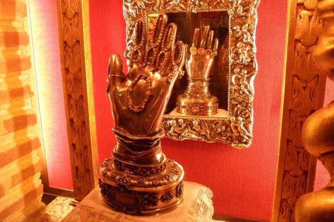 Fate of St. Teresa of Ávila’s left hand to be determined in coming months – #Catholic – A lack of vocations threatens the closure after more than a century of the Discalced Carmelite monastery in Ronda, Spain, which houses the left hand of St. Teresa of Ávila. The relicʼs final destination will be decided in the coming months.The monastery’s numbers dwindled in recent years from nine to four sisters — one of them with Alzheimerʼs. Since the COVID-19 pandemic, five have passed away due to old age and various medical conditions.According to the apostolic constitution Vultum Dei Quaerere, promulgated by Pope Francis in 2016, the minimum number of sisters required to maintain a community is six; otherwise, the remaining members must join other, larger communities.The nuns have not been able to find two more sisters despite efforts to publicize their need. As a result, the four remaining sisters from Ronda will move to other communities, and the most important relic housed in their convent will have to be relocated.Since 1924, the Carmelites have occupied a former Mercedarian convent founded in the 16th century but which was expropriated in the 19th century during the processes known in Spain as “desamortización,” the confiscation and sale of Church properties by the government.An incorrupt relic after 444 yearsThe relic of the incorrupt left hand of St. Teresa, a Carmelite reformer and doctor of the Church, was separated from her body in 1582. Following various historical twists and turns, it wound up with a religious community in Portugal.In 1910, a decree expelled religious orders from that country; consequently, the Carmelites fled to Spain, taking the relic to Ávila. When the Portuguese community was reestablished in Ronda, they requested the relic’s return.With the outbreak of the Spanish Civil War in 1936, militiamen from the Red Army forced the nuns to hand over the relic. Shortly thereafter, it was recovered by General Francisco Franco’s Nationalist Army and was moved to Burgos, the general’s headquarters, where he kept it until his death.In January 1976, the relic returned to the convent in Ronda, which now faces closure.The relic’s final destination remains uncertain, although there has been speculation about its return to Alba de Tormes, the saintʼs birthplace and the location of the rest of her body, which also remains incorrupt after 444 years. If the left hand were to return to Alba de Tormes, all of St. Teresa’s mortal remains would be reunited once more, after more than four and a half centuries.However, sources from the Iberian Province of the Discalced Carmelites have told ACI Prensa, the Spanish-language sister service of EWTN News, that a definitive decision has not been made on the matter.The canonical process for closing the Ronda monastery has not yet concluded and ultimately depends on the Vatican. The process is expected to be completed by early 2027.Also, the remaining nuns in Ronda, who will determine the fate of the relic, must now discern if they want to remain together and, if so, must ask to join one of the convents of the Our Lady of Mount Carmel Federation to which they belong.Likewise, they must determine the fate of the other belongings owned by the community.St. Teresa’s left hand could go to one of the monasteries where the four nuns settle or be entrusted to a diocese or the Carmelite motherhouse.This story was first published by ACI Prensa, the Spanish-language sister service of EWTN News. It has been translated and adapted by EWTN News English.