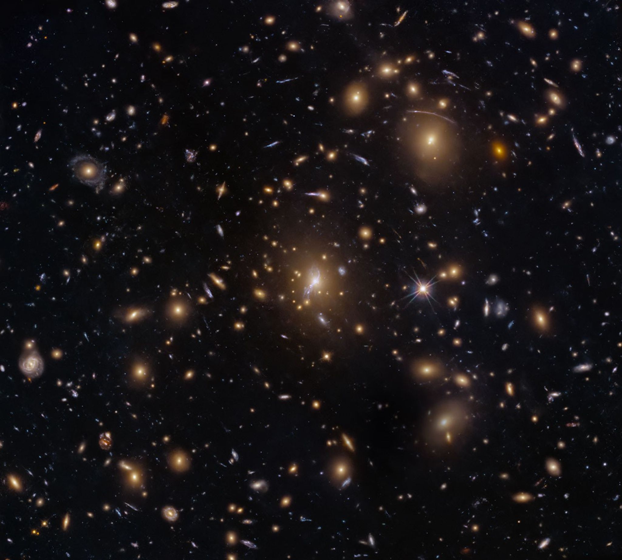 Hubble Sees Swarm of Galaxies – This NASA Hubble Space Telescope image features the galaxy cluster MACS0329-0211.