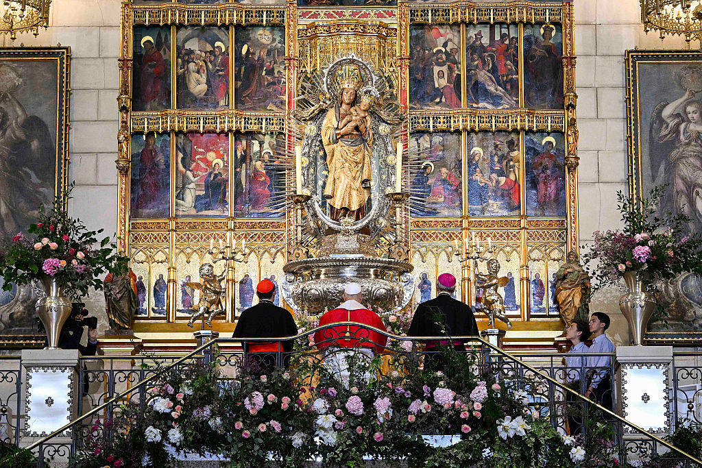 Pope Leo XIV honors Our Lady of Almudena with Golden Rose, reflects on Spain’s Christian heritage #Catholic For more than a thousand years, generations of Catholics in Madrid have turned to Our Lady of Almudena in times of celebration, hardship, and prayer. On June 8, that enduring devotion received one of the Church’s highest marks of recognition when Pope Leo XIV bestowed a Golden Rose upon the historic statue.“As a symbol of the pope’s filial love for the Virgin Mary, I will place a Golden Rose at her feet,” Leo said during a ceremony at Madrid’s Cathedral of Santa María la Real de la Almudena.The papal honor — one of the highest distinctions a pope can bestow upon a Marian image or shrine — recognizes the deep devotion generations of Spanish Catholics have shown to the Blessed Virgin under the title of Almudena.The exact origin of the gifting of a Golden Rose is unknown, although it is considered one of the oldest papal traditions. The earliest reliable record dates to 1096, when Pope Urban II sent one to Fulcone d’Angers. Hidden in the citadel wallAddressing the faithful gathered in the cathedral, Leo reflected on the image’s unique place in Madrid’s history.“For centuries, countless generations of Madrileños have venerated this image of the Blessed Virgin Mary holding her divine Son in her arms and presenting him to us,” the pope said.According to long-standing tradition, the devotion dates to the early centuries of Christianity in Spain. When Muslim forces conquered much of the Iberian Peninsula in A.D. 712, Christians in Madrid reportedly concealed the statue within the city’s defensive walls to protect it from destruction. The image remained hidden for centuries as Christian kingdoms gradually sought to reclaim territories across the peninsula during the Reconquista.The wall that fell In 1083, after King Alfonso VI of Castile recaptured Madrid, Christians searched for the long-lost statue. Tradition holds that after days of prayer, a section of the city wall suddenly collapsed, revealing the image preserved within. Witnesses reported seeing lights near the site, and the statue was discovered largely intact despite centuries of concealment.Recalling the story, Leo noted that “during challenging periods for the Christian community, the statue of the Virgin Mary was hidden in a niche of the citadel wall for protection. It remained concealed for some time, until parts of the wall collapsed and it was miraculously discovered intact.”The title “Almudena” derives from the Arabic word “al-mudayna,” meaning “citadel” or “fortress,” a reference to the location where the image was found.A message for today In his homily, the pope used the collapse of the wall as a spiritual lesson for modern society.“It was thanks to a collapsed wall that the Mother was reunited with her people,” Leo said. “This event is providential, because it points to the path that Jesus, through his most holy mother, invites us to follow.”Leo connected that image to challenges facing the modern world, observing that “there are still many walls that do not protect but rather divide, separate, and isolate.”The ceremony also highlighted the popeʼs connection to Spain, a nation whose Catholic heritage has profoundly shaped the history of the Church. By honoring one of Spain’s most beloved Marian images, the pontiff underscored the enduring importance of popular Marian devotion and the Christian roots that continue to influence Spanish culture.Renewing faith and hope Beyond its historical significance, the story of Our Lady of Almudena continues to resonate with Catholics today. The devotion recalls themes of perseverance, hope, and trust in God’s providence, themes Pope Leo himself highlighted as he encouraged the faithful to remain steadfast in faith, charity, and hope.Calling the devotion a source of hope, Leo described it as “a sign of the Christian roots that characterize you and give you life, but also of the great hope which continues to motivate you to move forward.”He concluded by encouraging Catholics to remain steadfast in faith, charity, and hope, asking that the intercession of Our Lady of Almudena strengthen believers in their love for Christ and help them “form bonds and restore the universal language of communion, fraternal love, and harmony.”