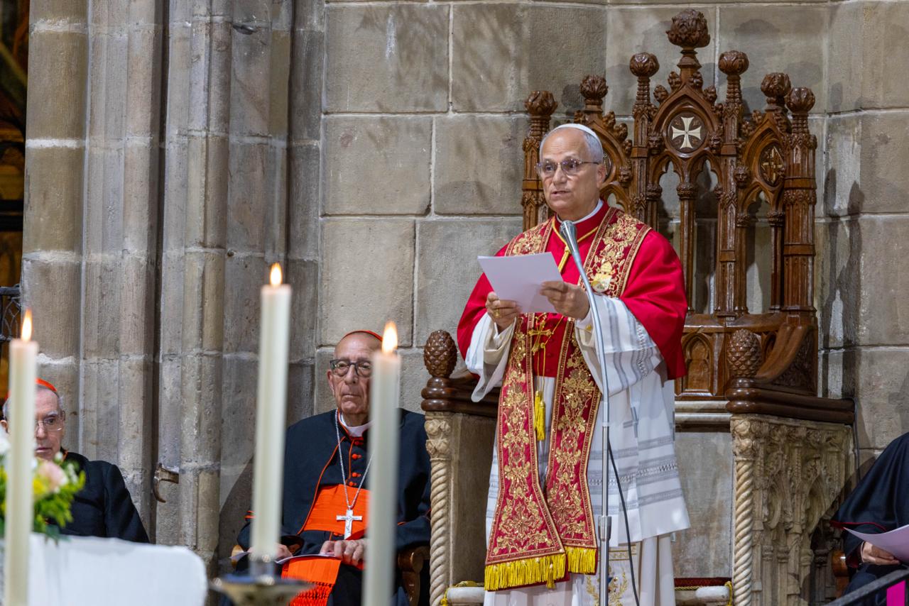 Pope Leo XIV in Barcelona calls Catholics to be martyrs of unity #Catholic BARCELONA, Spain — Pope Leo XIV dedicated Tuesday morning to thanking the thousands of volunteers who helped organize his apostolic journey to Spain before heading to Barcelona to touch the ancient traces of the country’s deeply rooted Christian faith.At the Cathedral of the Holy Cross and St. Eulalia, whose construction began at the end of the 13th century on the site of early Christian and Romanesque churches and which became, a century later, one of the most important jewels of European Gothic architecture, the pope prayed Midday Prayer with about 500 faithful.Hundreds more waited outside the cathedral to show their affection, many waving Vatican flags.The crowd erupted with excitement at his arrival. The pontiff was accompanied by Cardinal Juan José Omella, archbishop of Barcelona, who gestured with his hands to indicate to the people waiting outside that the pope had to leave. The plane carrying Leo XIV had landed in the Catalan capital 40 minutes late.During the ceremony, the pope sat in the oldest chair — the cathedra, or bishop’s seat — in the city that is still in use, dating at least to the cathedral’s consecration in 1058, according to recent research.In his homily, Leo XIV called Catholics to be builders of communion.“Dear brothers and sisters: it is in this spirit that we too, in a world torn apart by wars and divisions, in a society that is increasingly fragmented and individualistic, wish to be ‘martyrs’ — that is, witnesses and prophets of unity, of welcome, of harmony and of peace, even at the cost of sacrifice and renunciation,” the pope said.It was the first time during the trip that Leo XIV pronounced several phrases in Catalan, the language proper to Catalonia, co-official with Spanish and the main language of the regional administration.A symbol of Catalan cultural identity, the language to be used by the pontiff during the events scheduled in Barcelona had become the subject of public debate in Catalonia in recent days.The controversy intensified after it emerged that the blessing of the Tower of Jesus Christ at the Sagrada Familia — one of the central moments of the visit — would be conducted mainly in Spanish.In the Congress of Deputies, where the pope delivered an unprecedented address Monday, Junts per Catalunya lawmaker Miriam Nogueras asked him to speak Catalan.“It is important for each of us not to allow anything to destroy the unity in which God has established us and toward whose fullness he leads us day by day,” the pontiff said, alternating Catalan and Spanish in the homily.Leo XIV cited two addresses by his predecessor, Pope Francis, who never visited Spain but often expressed affection for the country.On the occasion of the inauguration of the Tower of the Virgin Mary at the Basilica of the Sagrada Familia on Dec. 8, 2021, Francis sent a message recalling that the Church “is the fruit of an act of love that precedes her and comes from God. Above all, she grows by allowing herself to be loved by him, united, with a humble and grateful heart, because only those who allow themselves to be loved by God can build, together with others, the works of love.”One year later, the Argentine pope told seminarians of the Archdiocese of Barcelona during a pilgrimage to Rome: “Never cease to savor and remember this love of predilection which pours and will pour itself abundantly into your heart.”Leo XIV structured his homily around the image of the Catholic Church as both beloved bride and body, with all believers as members of a single organism.The Spirit, he said, “impels us, as parts of a single living structure, not only to give ourselves unreservedly wherever Providence calls us, but to do so according to God’s designs, in obedience and trust.”Just as in a body, he continued, “so too among us there are members who are stronger and others who are weaker; some are visible, performing functions that are evident to the outside world, while others are hidden, working from within — in some cases without ceasing and carrying out vital functions without anyone taking notice.”The pope said there are many possible images to “illustrate the variety and importance of the roles and missions we find among ourselves,” but the message is always the same.“In the richness of the gifts we have received, we are strong because we are united, and we are united because we are animated by the same Spirit, the Spirit of Christ, who is the Spirit of communion for the salvation of all,” he said.Upon arriving, Leo XIV was received by Omella. After the greeting, the cardinal led him to the Chapel of the Blessed Sacrament for a brief moment of personal prayer.On his way to the altar, the pope passed by the baptismal font, built in 1433. It was in that baptistery that the first six Indigenous people brought from the Americas by Christopher Columbus received the sacrament of entrance into the Church, as a plaque in the chapel recalls.All of this forms part of the cathedral’s history, which inherits a tradition of worship in this part of Barcelona dating back to the fourth century.Leo XIV’s final act inside the cathedral was to descend to the crypt, where the tomb of the Roman martyr St. Eulalia, co-patroness of Barcelona, is located.Before her martyrdom, the young saint was said to have tended geese. For this reason, 13 geese are kept today in the cathedral cloister in her honor, recalling both her 13 tortures and the age at which she died for the Lord.The pontiff also spoke of “so many other martyrs” and called the faithful to respond with “our ‘yes,’ ready if necessary to die to ourselves, to lose ourselves in order to find ourselves again, to renounce the superfluous in order to build upon what is essential and lasts forever.”“This is what the crucified One teaches us,” the pope said. “This is what the Apostle Paul and the examples of the saints invite us to do.”The pope ended his homily by invoking Mary in Catalan: “Santa Maria de la Mercè, pregueu per nosaltres” — “Our Lady of Mercy, pray for us.”This story was first published by ACI Prensa, EWTN News’ Spanish-language sister service. It has been translated and adapted by EWTN News English.