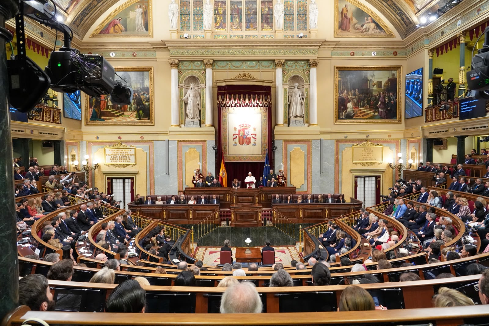 Pope Leo XIV tells Spain’s parliament every human life must be protected #Catholic MADRID — Pope Leo XIV made history Monday by becoming the first pope to address Spain’s Congress of Deputies, delivering a forceful appeal to the country’s political class to defend human dignity and protect life “from conception to its natural end.”The June 8 address, given before about 700 guests amid tight security, drew a standing ovation that lasted nearly seven minutes, with shouts of “Long live the pope!” echoing through the chamber.In his speech, Pope Leo warned lawmakers not to subordinate human dignity to “shifting social consensus or the whims of the majority at any given moment,” insisting that “every truly just society is built upon the recognition of the inviolable dignity of the human person.”“In this sense, if life ceases to be recognized as a fundamental value, what future can our societies have?” the pope asked. “Can a community that casts into the shadows the unborn child, the elderly, the sick, those who suffer in silence, or those who depend entirely on the care of others be called fully just?”“The defense of human life is neither a partisan issue nor a confessional interest: it is a goal of civilization,” he said.The pope’s remarks came as Spain’s socialist-led government has been advancing efforts to enshrine abortion protections in the country’s Constitution. Such a reform would require broad parliamentary consensus, including support from the center-right People’s Party.“Every human life must be recognized and safeguarded from conception to its natural end, in every circumstance of its existence,” Pope Leo said. “When this certainty is obscured, the most vulnerable are the first victims, and the law loses its deepest meaning: to serve and protect every person.”“For this reason,” he added, “the moral greatness of a nation is manifested, above all, in its capacity to accompany, protect and love those lives that are most fragile.”The pope also defended the family as “the primary human reality and the natural foundation of the community,” saying that “where the family is upheld, the spiritual and social stability of nations is also strengthened.”“The family will always be the first school of humanity, where one learns, before anywhere else, the basic grammar of living together: welcoming life, caring for others, forgiving, serving and belonging,” he said.Pope Leo drew on Spain’s intellectual and Catholic heritage, citing Cervantes, St. Teresa of Ávila, Miguel de Unamuno and the School of Salamanca, especially the 16th-century Dominican friar Francisco de Vitoria.From that tradition, he said, Spain helped shape “a legal and moral consciousness capable of remembering that authority always entails responsibility and that every human being must be recognized as a subject of rights and duties.”The pope said that legacy remains alive whenever lawmakers ask “how to ensure that what is possible is just, that what is legal is truly humane, and that the will of the majority safeguards those goods that belong to all and respects that which no majority can legitimately violate.”He also cited his recent encyclical “Magnifica Humanitas,” published May 25, saying that in an age of artificial intelligence, biotechnology and rapid technological change, political discernment must focus on “the place of the human person in our decision making.”The pope devoted part of his address to migrants and refugees, a major theme of his trip to Spain, which will conclude with visits to Tenerife and Las Palmas in the Canary Islands, a key entry point to Europe for migrants.“The situation of migrants and refugees calls for a response that focuses on people, addresses the root causes that force them to leave, and goes beyond the mere management of migration flows,” he said.He called for “safe and legal pathways, a respectful welcome and real opportunities for integration,” while also promoting “the right to remain in one’s own land,” so that no one is forced to leave home because of war, insecurity, poverty or the effects of the climate crisis.Pope Leo also warned that many migrants remain “prey to traffickers and smugglers who take advantage of their desperation,” calling for stronger prevention, rescue and assistance efforts.“No nation can face a challenge of this magnitude on its own,” he said.Turning to global conflict, Pope Leo said the world is undergoing “a profound spiritual and cultural crisis” marked by violence, polarization and mistrust.“Every war constitutes, ultimately, a painful defeat of the capacity to negotiate and also of that common human consciousness that recognizes bonds of justice among nations,” he said.“Weapons may impose a temporary silence; but they can never build a genuine and lasting peace,” the pope said, warning that “in various parts of the world — and in Europe as well — rearmament is once again being presented as an almost inevitable response to the fragility of the international situation.”The pope also warned against the use of artificial intelligence in warfare, saying new technologies in the military sphere require “rigorous ethical oversight, so that decisions regarding life and death are never left to automated systems nor removed from the moral responsibility of the human person.”Addressing Spain’s polarized political climate, the pope urged lawmakers to resist contempt for political opponents.“Political pluralism should not degenerate into the constant disparagement of one’s adversary,” he said. “In a mature society, even conflict can become a path to peace, when differences are softened by listening and directed toward recognizing the needs, aspirations and capabilities of all.”“Firmness does not require contempt; disagreement does not entail humiliation,” he added.Only two left-wing parties, Podemos and the BNG, which together account for six lawmakers out of more than 600 parliamentarians, chose not to attend the pope’s address.Pope Leo also made a strong appeal for religious freedom, calling freedom of thought, conscience and religion “a fundamental right that protects the most intimate sphere of the person.”“The freedom upon which the contemporary state is built, if it is authentic, recognizes the religious dimension of the human person, respects it and protects it legally,” he said. Authentic freedom, the pope added, “ensures that faith is not a reason for which a person has to forfeit his or her contribution to society.”“Faith does not seek to impose itself through privileges or coercion; yet neither can it be silenced as if it were irrelevant to public life,” he said.The pope also defended the sacramental seal of confession, saying it “holds special importance for the Catholic Church” and forms part of the broader sphere of religious freedom.“To protect it legally, as is done in a similar way in some professions, means preserving a sacred space of inner freedom, where the believer can open his or her soul to God without fear of external pressures,” Pope Leo said.The remarks came shortly after French bishops criticized a June 1 proposal in France’s National Assembly that they said could have endangered the seal of confession. The proposal was later withdrawn.Near the end of his address, the pope invited Spanish lawmakers to “lift your gaze to the world around you,” not to escape reality, but to remember that every public decision “affects real people, especially those who have less power to make their voices heard.”“A law does not attain its true greatness merely by having been formally enacted,” he said. “It attains it when, in addition to being valid in form, it can stand before the dignity of the person and pass that test without shame.”The pope concluded with a blessing for Spain, praying that the nation “never lose sight of its roots nor the courage to look to the future.”“May Spain continue to be a land of encounter, of culture, of solidarity and of hope,” he said. “And may its public life always know how to unite the firmness of convictions with the nobility of dialogue and the greatness of service.”This story was first published by ACI Prensa, the Spanish-language sister service of EWTN News. It has been translated and adapted by EWTN News English. Pope Leo XIV tells Spain’s parliament every human life must be protected #Catholic MADRID — Pope Leo XIV made history Monday by becoming the first pope to address Spain’s Congress of Deputies, delivering a forceful appeal to the country’s political class to defend human dignity and protect life “from conception to its natural end.”The June 8 address, given before about 700 guests amid tight security, drew a standing ovation that lasted nearly seven minutes, with shouts of “Long live the pope!” echoing through the chamber.In his speech, Pope Leo warned lawmakers not to subordinate human dignity to “shifting social consensus or the whims of the majority at any given moment,” insisting that “every truly just society is built upon the recognition of the inviolable dignity of the human person.”“In this sense, if life ceases to be recognized as a fundamental value, what future can our societies have?” the pope asked. “Can a community that casts into the shadows the unborn child, the elderly, the sick, those who suffer in silence, or those who depend entirely on the care of others be called fully just?”“The defense of human life is neither a partisan issue nor a confessional interest: it is a goal of civilization,” he said.The pope’s remarks came as Spain’s socialist-led government has been advancing efforts to enshrine abortion protections in the country’s Constitution. Such a reform would require broad parliamentary consensus, including support from the center-right People’s Party.“Every human life must be recognized and safeguarded from conception to its natural end, in every circumstance of its existence,” Pope Leo said. “When this certainty is obscured, the most vulnerable are the first victims, and the law loses its deepest meaning: to serve and protect every person.”“For this reason,” he added, “the moral greatness of a nation is manifested, above all, in its capacity to accompany, protect and love those lives that are most fragile.”The pope also defended the family as “the primary human reality and the natural foundation of the community,” saying that “where the family is upheld, the spiritual and social stability of nations is also strengthened.”“The family will always be the first school of humanity, where one learns, before anywhere else, the basic grammar of living together: welcoming life, caring for others, forgiving, serving and belonging,” he said.Pope Leo drew on Spain’s intellectual and Catholic heritage, citing Cervantes, St. Teresa of Ávila, Miguel de Unamuno and the School of Salamanca, especially the 16th-century Dominican friar Francisco de Vitoria.From that tradition, he said, Spain helped shape “a legal and moral consciousness capable of remembering that authority always entails responsibility and that every human being must be recognized as a subject of rights and duties.”The pope said that legacy remains alive whenever lawmakers ask “how to ensure that what is possible is just, that what is legal is truly humane, and that the will of the majority safeguards those goods that belong to all and respects that which no majority can legitimately violate.”He also cited his recent encyclical “Magnifica Humanitas,” published May 25, saying that in an age of artificial intelligence, biotechnology and rapid technological change, political discernment must focus on “the place of the human person in our decision making.”The pope devoted part of his address to migrants and refugees, a major theme of his trip to Spain, which will conclude with visits to Tenerife and Las Palmas in the Canary Islands, a key entry point to Europe for migrants.“The situation of migrants and refugees calls for a response that focuses on people, addresses the root causes that force them to leave, and goes beyond the mere management of migration flows,” he said.He called for “safe and legal pathways, a respectful welcome and real opportunities for integration,” while also promoting “the right to remain in one’s own land,” so that no one is forced to leave home because of war, insecurity, poverty or the effects of the climate crisis.Pope Leo also warned that many migrants remain “prey to traffickers and smugglers who take advantage of their desperation,” calling for stronger prevention, rescue and assistance efforts.“No nation can face a challenge of this magnitude on its own,” he said.Turning to global conflict, Pope Leo said the world is undergoing “a profound spiritual and cultural crisis” marked by violence, polarization and mistrust.“Every war constitutes, ultimately, a painful defeat of the capacity to negotiate and also of that common human consciousness that recognizes bonds of justice among nations,” he said.“Weapons may impose a temporary silence; but they can never build a genuine and lasting peace,” the pope said, warning that “in various parts of the world — and in Europe as well — rearmament is once again being presented as an almost inevitable response to the fragility of the international situation.”The pope also warned against the use of artificial intelligence in warfare, saying new technologies in the military sphere require “rigorous ethical oversight, so that decisions regarding life and death are never left to automated systems nor removed from the moral responsibility of the human person.”Addressing Spain’s polarized political climate, the pope urged lawmakers to resist contempt for political opponents.“Political pluralism should not degenerate into the constant disparagement of one’s adversary,” he said. “In a mature society, even conflict can become a path to peace, when differences are softened by listening and directed toward recognizing the needs, aspirations and capabilities of all.”“Firmness does not require contempt; disagreement does not entail humiliation,” he added.Only two left-wing parties, Podemos and the BNG, which together account for six lawmakers out of more than 600 parliamentarians, chose not to attend the pope’s address.Pope Leo also made a strong appeal for religious freedom, calling freedom of thought, conscience and religion “a fundamental right that protects the most intimate sphere of the person.”“The freedom upon which the contemporary state is built, if it is authentic, recognizes the religious dimension of the human person, respects it and protects it legally,” he said. Authentic freedom, the pope added, “ensures that faith is not a reason for which a person has to forfeit his or her contribution to society.”“Faith does not seek to impose itself through privileges or coercion; yet neither can it be silenced as if it were irrelevant to public life,” he said.The pope also defended the sacramental seal of confession, saying it “holds special importance for the Catholic Church” and forms part of the broader sphere of religious freedom.“To protect it legally, as is done in a similar way in some professions, means preserving a sacred space of inner freedom, where the believer can open his or her soul to God without fear of external pressures,” Pope Leo said.The remarks came shortly after French bishops criticized a June 1 proposal in France’s National Assembly that they said could have endangered the seal of confession. The proposal was later withdrawn.Near the end of his address, the pope invited Spanish lawmakers to “lift your gaze to the world around you,” not to escape reality, but to remember that every public decision “affects real people, especially those who have less power to make their voices heard.”“A law does not attain its true greatness merely by having been formally enacted,” he said. “It attains it when, in addition to being valid in form, it can stand before the dignity of the person and pass that test without shame.”The pope concluded with a blessing for Spain, praying that the nation “never lose sight of its roots nor the courage to look to the future.”“May Spain continue to be a land of encounter, of culture, of solidarity and of hope,” he said. “And may its public life always know how to unite the firmness of convictions with the nobility of dialogue and the greatness of service.”This story was first published by ACI Prensa, the Spanish-language sister service of EWTN News. It has been translated and adapted by EWTN News English.
