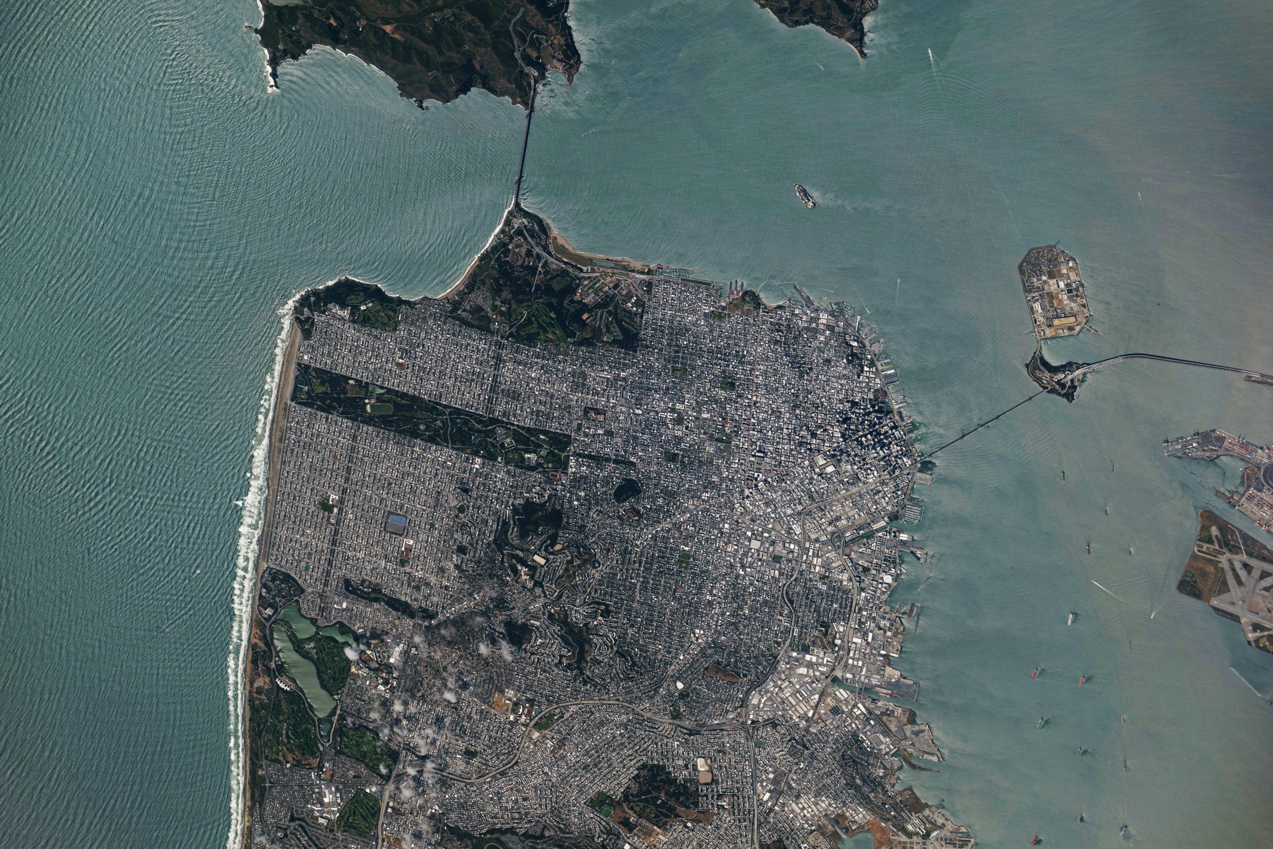 San Francisco’s Patchwork Streets – A period of unsettled weather brought scattered showers and thunderstorms to California’s Bay Area on May 27, 2026. That afternoon, a break in the clouds left downtown San Francisco and nearby communities beneath mostly cloud-free skies, allowing an astronaut aboard the International Space Station to take this photograph.