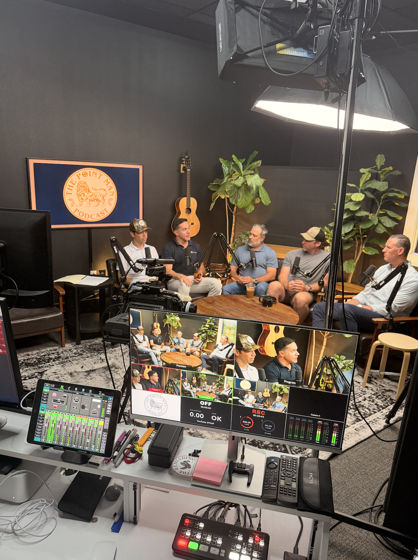 ‘The Church needs her sons’: Catholic podcast hosts call men to embrace fatherhood and faith #Catholic Samuel Blair and Jason Angelette are two of the five hosts of “The Point Man Podcast,” a podcast for Catholic men. Together, alongside Chris Price, Clint Capdepon, and Drew Pearson, they are fathers and husbands who share their knowledge and experience about navigating life today as Catholic men and as leaders of their families.Blair, a father of four, and Angelette, a widowed father of five, explained that the podcast is aimed at fathers and focuses on how masculinity and the sacramental life can be integrated. Describing themselves as a “mic’d up men’s group,” they try to foster a community to help men realize they’re not alone and encourage one another in their walk with the Lord.Ahead of Father’s Day, EWTN News spoke to the two men about how masculinity is perceived in today’s culture, what authentic masculinity looks like, and why fatherhood is such an important vocation in the life of the Church.(Editorʼs note: This interview was edited for clarity and length.)EWTN News: “Toxic masculinity” is a term used a lot in todayʼs culture. How would you each define authentic Catholic masculinity?Angelette: Jesus Christ. Thatʼs authentic masculinity. Jesus Christ fully reveals man to himself in his most high calling … the more that we model, imitate, and walk in the footsteps of Our Lord and Savior Jesus Christ, we will radiate a loving walk with our brothers and sisters in Christ in showing what real masculinity looks like.He tells the story of the prodigal son, which is the greatest short story ever told of what happens when, in the face of a father who is humiliated by his son, his son abandoned him, took the money, squandered the inheritance, and just left this complete stain on the family name, and how does he respond to it? Or when you see the compassion and the mercy that he shows the woman who is literally caught in the very act of adultery. Or you see when he embraces Peter after heʼs denied him three times and he gives him three chances to redeem himself and to show that mercy and that kindness and that humility and that gentleness.The heart of a man is a heart that has been set on fire by the Lord Jesus and he loves with gentleness and humility, not weakness in a sense of [being passive], but meekness in the sense of responding to the will of the Father.Blair: At the end of the day, when we die, the Lord doesnʼt ask us, “All right, well let me see your bank account, let me see the titles.” Itʼs “How well did you love?” And you cannot love if you donʼt receive love, which is to Jasonʼs point, he said it very succinctly, is Jesus Christ — he is the way, the truth, and life. So, modeling our lives after him and in that offering not only our wife, our children, our community, stability, offering our strength, warmth, validation because weʼve received that validation and love from the Father.Angelette: Toxic masculinity is men who are fighting the wrong fight. Men who have embraced the wrong identity, men who have abused the gifts and talents that theyʼve been given for themselves and not for others and for the kingdom.
 
 Samuel Blair, Jason Angelette, Chris Price, Clint Capdepon, and Drew Pearson film an episode of “The Point Man Podcast.” | Credit: Studio 7 at The Reminding
 
 Why is fatherhood such an important vocation in the life of the Church?Angelette: John Paul II, who wrote a play — he wrote five plays — and his last one was called “Radiation of Fatherhood.” And I feel like part of the gift of fatherhood is to radiate the fatherhood of God into the world and to our children.That is this beautiful gift that weʼve been given to participate in this way that God wants to reveal himself through us. Heʼs allowing us to participate — and not act like him, but to love like him, to love with a love like his.So as men, as husbands, as fathers, thereʼs this ability that through this masculine heart, this male heart, through this fatherhood, that we can love and reveal the love of God, the love of the father into the world.Satan hates that. I mean, the thing that destroys families is when fathers have abandoned their post and they leave. Look at the statistics of what happens when a father is not embracing his responsibility as the first herald of the faith, to lead their family in faith, and how hard it is for the faith to be passed on to the next generation.For Fatherʼs Day, what message would you like to share with fathers?Blair: Fathers, know that you’re unconditionally loved by God the Father and that the prodigal son points to that. And whether youʼre the younger son or the older son, he has this great inheritance for his boys, his sons.Not only should we enter into a relationship with Jesus for our own sake but for our wives, for our children, and ultimately the Church. The Church needs her sons fully engaged. Gone are the days you can just be on the sidelines.Angelette: You hear all the time that God loves you and unless youʼre drawing near to the Father, that just sounds like words. So, just avail yourself to really draw into prayer, to the sacraments, to connect with other men in Christ to not walk this road alone.If you want your heart on fire, draw near to the Sacred Heart and let his fire, let the heart of Christ, ignite your heart to the love that weʼre called to so we can truly love our families, truly love our children, and love our wives, and be the man that we know in our heart we want to be and that weʼre being called to be.