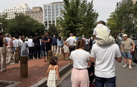 'Witness to the whole world': Families gather for Eucharistic procession in Washington, D.C. - #Catholic - Along K Street in Washington, D.C., amid a humid morning on June 6, Catholics from across the area gathered to adore the Eucharist as it processed through the nationʼs capital. Despite the heat and humidity, many parents and grandparents packed their little ones into strollers or baby carriers and brought them out to view the Eucharistic pilgrimage as it made its way through D.C. The local procession was a partnership between the Catholic Information Center and the National Eucharistic Pilgrimage. 
 
 Families participate in the National Eucharistic Pilgrimage as it makes its way through downtown Washington, D.C., on June 6, 2026. The pilgrimage began in Florida and will finish in Philadelphia later in the summer. | Credit: Gemma Flores/EWTN News
 
 “I really like taking my kids to the Eucharistic processions for Corpus Christi,” Theresa Cambell said while pushing Augustine, three years old, and Rowena, nine months, in a stroller in the procession. “I think practical things really help them understand the significance of what is going on.” Campbell, who lives in the Capitol Hill neighborhood, took her children to the Catholic Information Center procession last year. Though she wasn’t raised going to processions or adoration regularly with her family, Campbell said the tradition was important to her as she raises her own children so that they can better come to understand the Church. A big part of this, she said, was her own active participation.“Children have a very natural orientation towards liturgy, and I think that the reverence that everyone has in the tradition actually does most of the teaching,” Cambell said. “And then, you know, we do explain that it is the body and blood of Christ and that the procession is for Corpus Christi, and we try to tie that into the liturgical year.”Maria and Pedro Estrada of Reston, Virginia, practice similar worship habits with their four children. The couple moved to the United States from Argentina six years ago and grew up attending similar events with their families. Estrada said she and her husband take their children to adoration regularly and practice family prayer to get them interested in Jesus and the Church.“At home, we pray a lot,” Estrada explained. “We pray the rosary in front of our kids, and they see us and they try to imitate us. They’re very interested in Jesus and His love for us, and we explain that all the things we have, and the way we are, is because of Jesus, and because He loves us. And it’s nice to Him that we, you know, give Him some of the love He gave us.”Julie Enzler of Alexandria, Virginia, helped take her 15-month-old granddaughter through the procession while her daughter volunteered with the Catholic Information Center.“What I appreciate about the procession through the city is the witness that we can give to the whole world of our Eucharistic Lord present in the midst of us, and to bring the power of his love to the streets,” Enzler said. “It’s something we try to do in person every day, hopefully, but just to make Him present in the lives of people who wouldn’t necessarily find Him.”Enzler said that all her grandchildren are being raised in the Catholic Church and attending Corpus Christi processions, even though she herself did not growing up. This, she hopes, will help them to orient their lives toward God.Enzler said she knows how valuable it is to bring Christ with you wherever you go, whether that be spiritually or in actuality.“Because the Church is the body of Christ, we all need each other,” Enzler explained. “We all need the witness of new life in the body. And the children need the witness of adults doing things that might be uncomfortable.” “For old people, it’s uncomfortable on your knees,” she continued. “And for other ages, maybe it’s uncomfortable to be seen practicing your faith or witnessing to your faith in the Eucharist, which is something that’s not obvious without faith.”Enzler said that she feels the United States is poised to accept Christ at this moment, and that showing the next generation of Catholics what faithful adoration looks like can help spread this.“I’m really grateful to the [Catholic Information Center] for offering this opportunity and for the word of hope that this event brings to the streets of Washington, D.C. at a time where the country seems particularly open to the practice of faith and the witness of faith,” she said. “I know there’s a lot of prayers begging more and more graces, so I’m grateful,” she said. “There’s always the grace that we can count on, but we can’t see or quantify.”