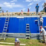 Mendham teens return from life-changing mission trip to Appalachia #Catholic - Forty-six teenagers and 22 adult chaperones from St. Joseph Catholic Parish in Mendham, N.J., recently returned from a weeklong mission trip to Paintsville, Ky., where they participated in St. Joseph’s 18th annual Teen Appalachia Mission Trip from June 21 to 27.
Partnering with Good Neighbors, Inc., a Paintsville-based nonprofit, the group completed critical home repair projects for families in need. The organization serves working families who do not qualify for government assistance, connecting them with volunteer groups, such as the St. Joseph mission team. In exchange for home repairs, participating families commit to financial literacy training and are encouraged to “pay it forward” by helping others in their community.
This year’s projects included repairing roofs, constructing home additions, installing drywall, replacing flooring, and completing other essential improvements that enhanced the safety, comfort, and stability of local homes.
While the physical work made an immediate impact, the mission also focused on building meaningful relationships. Volunteers shared meals, conversations, and time with the families they served, creating connections that extended beyond the construction projects.

Click here to subscribe to our weekly newsletter.

“This trip gives our teens the opportunity to build meaningful relationships while living out our God-given call to serve our sisters and brothers in need,” Mark Tosso, youth director at St. Joseph’s said. “It strengthens the sense of community within our parish and creates lasting connections with the wonderful families we meet in Kentucky.”
Avery Draeger, a junior at Villa Walsh Academy in Morristown, N.J., said, “Throughout this experience, I was overwhelmed with a feeling of gratitude and purpose.”
“In Paintsville, I felt that I strengthened my relationship with God, my peers, and the family and community in which we were helping. Giving these families back a sense of security to return to a safer home was an opportunity of a lifetime,” Draeger said.
Max Cirillo, a junior at Delbarton School, also in Morristown, agrees.
‘My experience on the mission gave me the opportunity to reflect internally and externally, form new relationships with peers and the families we were helping, and to grow in my faith with God, all while gaining an appreciation for the little things that are taken for granted every day. It was incredible!” Cirillo said.
“The Appalachia mission is truly one of a kind,” adds Mendham senior Max Krolikiewicz. “The lessons that we learn on the trip are truly something that I will remember forever. I feel that I build so many bonds with new people while strengthening my bonds with those I have already built. The strongest bond that I have built is my relationship with the Lord. There are so many ways that he is felt and seen in the work that we do, and it really has helped me to go beyond my faith and continue to want to pursue it.”
And it was not just the teens on the trip that benefitted, said parent chaperone and trip director Scott Cirillo of Mendham.
“The opportunity to be part of this mission on behalf of St Joseph’s is a privilege. It fills my bucket every year. Our time together and the work we do for deserving families in Paintsville, Ky., is grounded in our faith and knowledge that the Holy Spirit has brought us there to share the gifts God has given us. The overwhelming gratitude and response from the families we serve that we were an answer to their prayers says it all,” Cirillo said.
 [See image gallery at beaconnj.org]