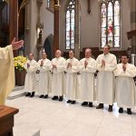 Newly ordained permanent deacons are serving with Christ’s heart #Catholic – In Scripture, the number 40 is far more than a measure of time. It signifies a sacred season of prayer, preparation, testing, transformation, and new beginnings. Noah witnessed 40 days of rain before the Earth was renewed. Moses spent 40 days on Mount Sinai before receiving the Law. The Israelites wandered for 40 years before entering the Promised Land. Jesus fasted for 40 days in the desert before beginning his public ministry. After his resurrection, Christ remained with his disciples for 40 days before his ascension, preparing them to continue his mission.
As I reflected on the first 40 days after our ordination to the permanent diaconate on May 30, I invited my brother deacons from my ordination class to share their experiences. Together, our reflections revealed a beautiful truth: although our ministries differ, our calling is the same — to serve with the heart of Jesus Christ.
Contributors to this column are Deacon Elmer Lopez Maximo of Sacred Heart Parish in Rockaway, N.J.; Deacon Stephen Deehan of St. Luke Parish in the Long Valley neighborhood of Washington Township, N.J.; Deacon Paul DePinto of St. Joseph Parish in Lincoln Park, N.J.; Deacon Timothy Dunmyer of St. Jude Parish in Hopatcong, N.J.; Deacon James Gillespie of St. Catherine of Siena Parish in Mountain Lakes, N.J.; Deacon Tobi Ippolito of Holy Family Parish in Florham Park, N.J.; Deacon Tom Kimble of St. Jude Parish in the Budd Lake neighborhood of Mount Olive Township, N.J.; and Deacon Gregory Marchesi of St. Therese Parish in the Succasunna neighborhood of Roxbury Township, N.J.
Living the Gospel Through Service
The transition from ordination to ministry happened almost immediately. The joy of ordination quickly gave way to the privilege of serving God’s people.
Many of us began preaching within days of our ordination, and we regularly proclaim the Gospel in our respective parishes.
Baptism has been one of the greatest joys of our new ministry. Deacon Kimble’s very first baptism was his grandson Tommy’s into the Church. Deacons Gillespie, DePinto, Marchesi, Ippolito, and Deehan had the privilege of celebrating baptisms in the first weeks of ministry.
I was blessed to celebrate my first baptism on the Feast of St. Benedict. Watching a child become a son of God while an entire family renewed their faith made the celebration memorable.
Our ministry has brought us joys and sorrows. Some celebrated, assisted or preached at weddings. Deacon DePinto blessed two couples celebrating their 60th wedding anniversaries, a beautiful witness to the enduring grace of Christian marriage. They also have presided over funeral vigils, assisted at funeral Masses, and conducted their first committal services.
Deacon Deehan said he blesses at least one person every day, seeing each blessing as an opportunity to renew hearts and strengthen faith. The new deacons have also blessed homes, religious articles, parishioners after Mass, and individuals asking for prayers.
The deacons have found that some of the most meaningful moments happen quietly, accompanying Christ’s people in hospital rooms, parish meetings, Eucharistic adoration, holy hours, conversations after Mass, and simple encounters with people seeking encouragement.
Moments That Will Stay With Us
When I asked my classmates about their most memorable experiences so far, their responses reminded me that ministry is never about numbers; it is always about people served by Christ.
Deacon Marchesi said that moment was when he preached his first homily, with his father present. Deacon DePinto said it was the overwhelming gratitude parishioners expressed after his first homily, thanking him for answering God’s call.
Deacon Dunmyer recalls Trinity Sunday, when he delivered his first Sunday homily and realized that years of prayer, discernment, and formation had become a living reality.
Deacon Deehan finds his greatest joy in witnessing lives renewed through simple, faithful presence at St. Luke’s. He said, “The best thing I find that I do is re-energizing people’s faith through my commitment to them through God.”
I had the privilege of preaching at my pastor’s farewell Mass before his transfer to another parish. That day, I realized that a deacon is often invited into the holiest moments of people’s lives, not to be the center of attention but to help others encounter Christ.
What We Are Learning
Although each of us serves in different parishes and ministries, our reflections reveal remarkable unity. Deacon Kimble said deacons receive the grace of Holy Orders to share the Good News more effectively. Deacon Marchesi said, “Being a deacon is a humbling ministry.”
Deacon DePinto reflected, “A deacon is a humble servant,” striving each day to follow Christ in both word and example. Deacon Ippolito said being a deacon involves “service to others in the name of Jesus.”
Deacon Dunmyer admitted that he still has much to learn and prays for the wisdom to serve God’s people. Deacon Gillespie said, “Being a deacon means that I will be in a ministry of service, meeting the needs of my parish, community, and the diocese.”
Deacon Deehan said that through a deacon’s compassionate presence, attentive listening, and faithful accompaniment, God often brings people back to the Church one encounter at a time.
One of the greatest blessings of these first 40 days has been realizing that ordination did not mark the end of our journey together; it marked the beginning of a lifelong fraternity — a brotherhood in Christ, strengthening one another. We gather weekly on Zoom to pray, make sure we see each other at family gatherings and diocesan events, and have monthly dinners with our wives and families.
Looking Ahead
These first 40 days have taught us that a deacon’s ministry is measured not by statistics but by faithfulness. Whether preaching to a full church, baptizing a child, blessing couples celebrating 60 years of marriage, comforting grieving families, accompanying hospital patients, or quietly praying with someone after Mass, each act of service becomes an opportunity to make Christ present.
We remain grateful to Bishop Kevin J. Sweeney, our pastors, formation directors, mentors, families, and parish communities, whose prayers continue to sustain us. Above all, we thank God for the gift of Holy Orders and the privilege of serving His Church.
Our prayer is that the Lord will continue to form our hearts after His own, so that in every word we proclaim, every person we accompany, and every act of charity we perform, others may encounter not us but Jesus Christ, the Servant of all. That is the final lesson of these first 40 days: our ministry is meant to lead others to Christ.

Click here to subscribe to our weekly newsletter.

&nbsp;