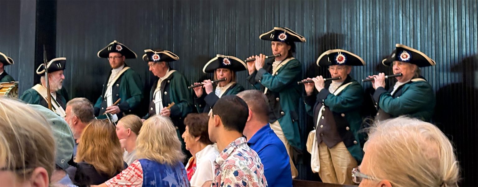 St. Thomas the Apostle Parish hosts heartfelt 4th of July concert #Catholic – St. Thomas the Apostle Parish in the Oak Ridge neighborhood of Jefferson Township, N.J., celebrated America’s 250th anniversary with a concert organized by Dr. Eric Stroud, the parish’s music minister and organist. The adult, children, and handbell choirs sang and were joined by performances by visiting soloist Richard Rossback, percussionist Steve O’Toole, and Hackettstown’s Colonial Musketeers, a local fife and drum group.
The Colonial Musketeers started the concert with an outdoor parade around the church. The concert opened with “The Star-Spangled Banner” and included patriotic selections “America the Beautiful,” “God Bless America,” and “The Battle Hymn of the Republic.” Numerous military marches were also performed along with a rendition of “God Bless Our Countrymen” composed by St. Thomas parishioner Kathy Murphy.
The concert featured a salute to the Armed Forces on the organ performed by Dr. Stroud. Veterans and active-duty members of the Army, Navy, Marines, Air Force, Coast Guard, and Space Force stood and were recognized as their respective service songs played. Several service members attended in uniform, including Air Force veteran and pastor of St. Thomas the Apostle and St. John Vianney parishes, Father Ben Williams. Luke and Max Williver, young Boy Scouts and parishioners of St. Thomas, led the pledge of allegiance.
Click here to subscribe to our weekly newsletter.
The parish is grateful to American Legion Post 423 Milton, who served as the Color Guard for the concert.
The Knights of Columbus Council 5510 hosted a celebratory summer barbecue for all who attended. The parish expresses its appreciation to the Knights, and especially Chefs Mike Murphy and Jim Zajdel, for the party in the festively decorated Msgr. Fitzpatrick Social Hall. St. Thomas the Apostle Parish hosts heartfelt 4th of July concert #Catholic – St. Thomas the Apostle Parish in the Oak Ridge neighborhood of Jefferson Township, N.J., celebrated America’s 250th anniversary with a concert organized by Dr. Eric Stroud, the parish’s music minister and organist. The adult, children, and handbell choirs sang and were joined by performances by visiting soloist Richard Rossback, percussionist Steve O’Toole, and Hackettstown’s Colonial Musketeers, a local fife and drum group.
The Colonial Musketeers started the concert with an outdoor parade around the church. The concert opened with “The Star-Spangled Banner” and included patriotic selections “America the Beautiful,” “God Bless America,” and “The Battle Hymn of the Republic.” Numerous military marches were also performed along with a rendition of “God Bless Our Countrymen” composed by St. Thomas parishioner Kathy Murphy.
The concert featured a salute to the Armed Forces on the organ performed by Dr. Stroud. Veterans and active-duty members of the Army, Navy, Marines, Air Force, Coast Guard, and Space Force stood and were recognized as their respective service songs played. Several service members attended in uniform, including Air Force veteran and pastor of St. Thomas the Apostle and St. John Vianney parishes, Father Ben Williams. Luke and Max Williver, young Boy Scouts and parishioners of St. Thomas, led the pledge of allegiance.
Click here to subscribe to our weekly newsletter.
The parish is grateful to American Legion Post 423 Milton, who served as the Color Guard for the concert.
The Knights of Columbus Council 5510 hosted a celebratory summer barbecue for all who attended. The parish expresses its appreciation to the Knights, and especially Chefs Mike Murphy and Jim Zajdel, for the party in the festively decorated Msgr. Fitzpatrick Social Hall.