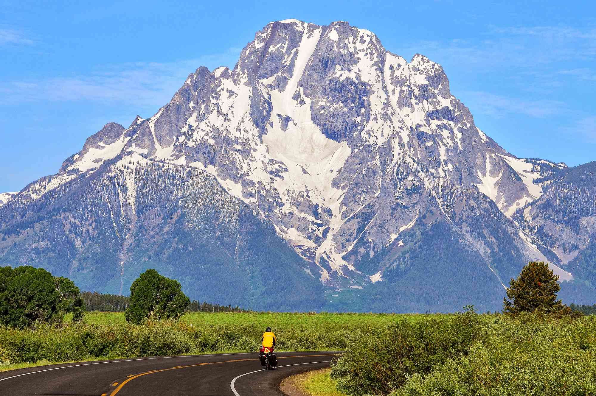 This Scenic 496-mile Bike Route Passes a National Park, an Elk Refuge, and Hot Springs #Travel Pedal through Grand Teton National Park along this stunning Wyoming cycling trail.
