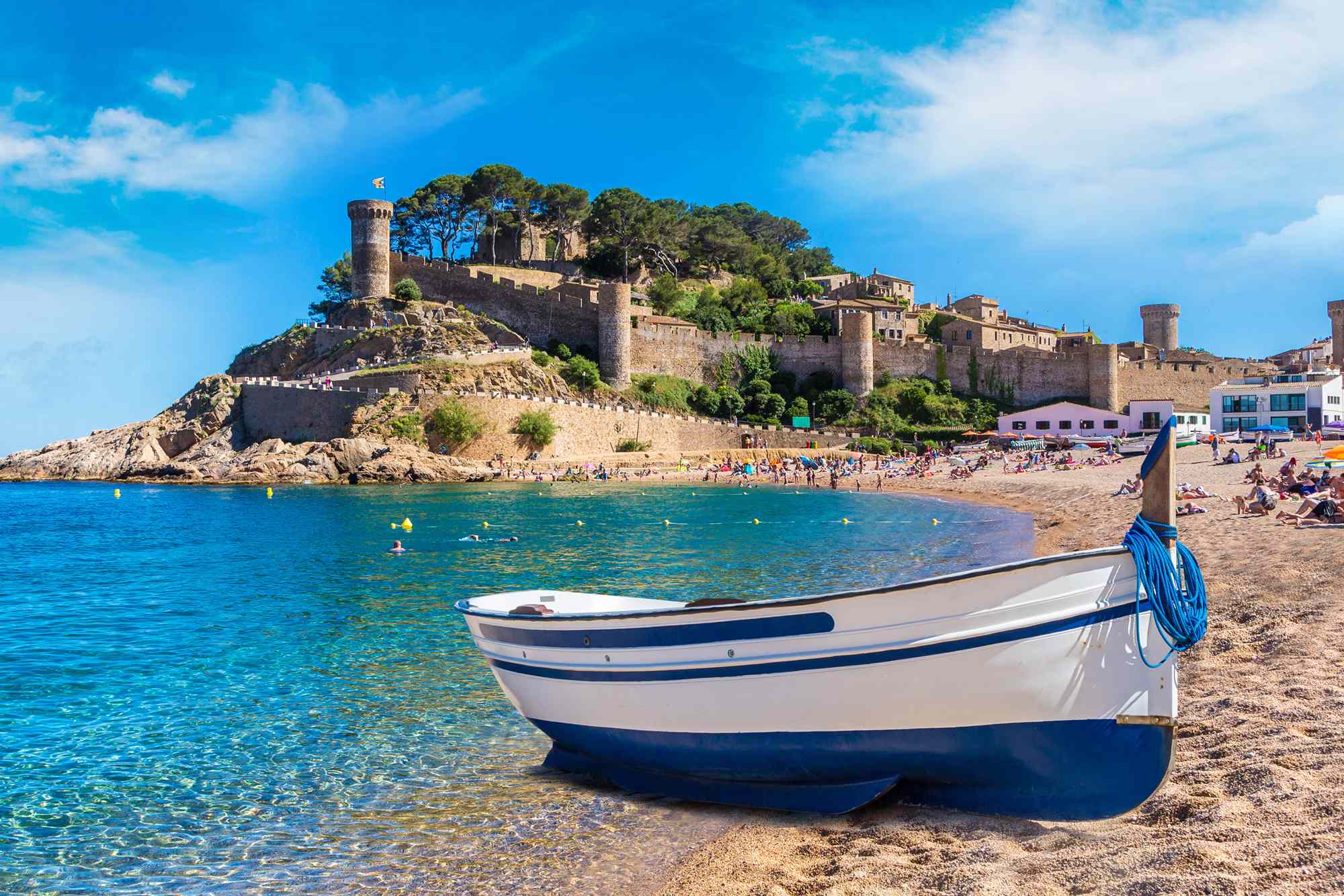 9 Best Beach Towns to Visit in Spain, According to Locals and Travel Experts #Travel Take your pick of these seaside gems with historic charm, stunning coastal scenery, and incredible gastronomy.