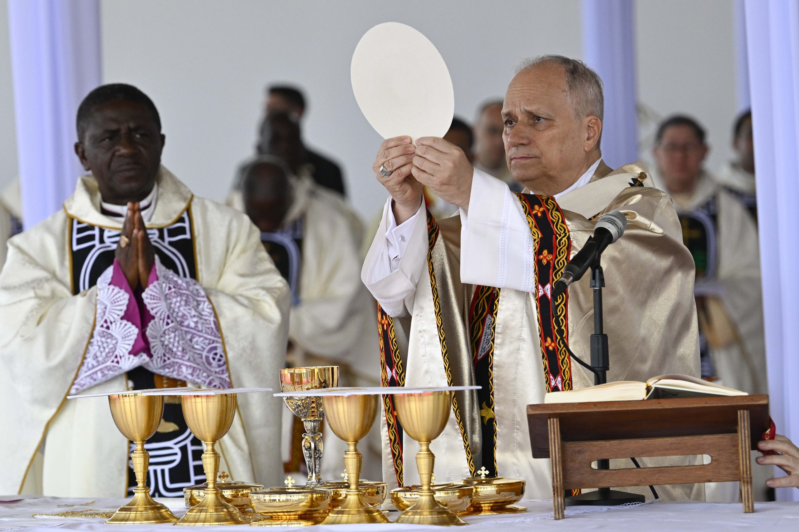EWTN News explains: How is Catholic Communion bread made? – #Catholic – The Second Vatican Council referred to the Eucharist as “the source and summit of the Christian life,” St. Augustine referred to it as “a Divine storehouse filled with every virtue,” and St. Thérèse of Lisieux described it simply as “the sole remedy, if you want to be cured.”Yet though Christ in the Eucharist occupies a place of centrality in the Church, many Catholics may not ever stop to reflect on the bread that in the Mass becomes Christ — namely, how is this unique substance produced before it is brought to the altar?The question is not merely academic; in rare instances the local Church can run out of Communion hosts, as occurred in Cuba in June. All of Cuba’s hosts are produced by Discalced Carmelites at the Monastery of Santa Teresa and San José, but the lack of a reliable power supply there hindered production over the summer.Sister Ruth Starman, the head of altar bread production for the Benedictine Sisters of Perpetual Adoration in Clyde, Missouri, told EWTN News that the requirements for Catholic altar bread are dictated by the Code of Canon Law of the Church, specifically canon 924. The sisters’ abbey in Missouri has been producing altar bread for years and was the first U.S. producer of altar breads approved by the Vatican to make low-gluten hosts. Standard hosts, she said, “can be made of wheat and water only.” “Yeast is not allowed because that would make it leavened bread and Jesus used unleavened bread at the Last Supper,” she said. "Any other additives such as salt, honey, etc. would be forbidden.”In addition to the strict water-and-wheat requirements, Church law dictates that the bread must be “recently made so that there is no danger of spoiling.” Manufacturers, meanwhile, use special machines on which to bake the bread to ensure it is produced in the familiar uniform and thin style. “The baking machines have plates that may have designs on them or not,” Starman said. “The plates will produce a thin wafer sheet that will then need to be moistened in a dampener before being cut into the round hosts.” Breads that are not moistened “will shatter when cut,” she said. Special cutters, meanwhile, allow bakers to divide the bread into differently sized hosts including the smaller rounds intended for lay communicants and the larger portions for priests and bishops. As to why the bread is so thin and flat, Starman told EWTN News: “I donʼt have the answer for that but just conjecture. Because it is unleavened, the bread will be ‘flat’ anyway. However, I suppose with the invention of specialized baking equipment, where two baker plates close upon the batter, that probably started the more wafer-thin hosts."Starman said there have been “no major changes” to the process in recent years. “The Vatican does periodically have to remind priests and the Church at large that anything other than a wheat bread cannot be used,” she said. “Hosts made from rice, corn, or potato starch, for example, are considered invalid matter.” The low-gluten hosts at the abbey, she said, are made from two different wheat starches that have had most of the gluten removed. “The Church does not say how much wheat percentage a host must have, but only that it needs to have some amount to make it valid matter,” she said. Elsewhere the Church has stressed the need for hosts to be treated with reverence at every stage of the process. The instruction Redemptionis Sacramentum, promulgated in March 2004 by what was then the Congregation for Divine Worship and the Discipline of the Sacraments, states that the bread “should obviously be made by those who are not only distinguished by their integrity, but also skilled in making them and furnished with suitable tools.”In response to the shortage of Communion hosts in Cuba earlier this year, Church leaders in Panama sent 35,000 hosts to the island nation, while another 300,000 were sent from Puerto Rico.Archbishop José Domingo Ulloa Mendieta of Panama said at the time that the emergency shipment arose “in response to the difficulties several Cuban dioceses are facing in ensuring a supply of hosts.” The prelate called the hosts “an essential element for the celebration of the sacrament that constitutes the source and summit of the Christian life.” EWTN News explains: How is Catholic Communion bread made? – #Catholic – The Second Vatican Council referred to the Eucharist as “the source and summit of the Christian life,” St. Augustine referred to it as “a Divine storehouse filled with every virtue,” and St. Thérèse of Lisieux described it simply as “the sole remedy, if you want to be cured.”Yet though Christ in the Eucharist occupies a place of centrality in the Church, many Catholics may not ever stop to reflect on the bread that in the Mass becomes Christ — namely, how is this unique substance produced before it is brought to the altar?The question is not merely academic; in rare instances the local Church can run out of Communion hosts, as occurred in Cuba in June. All of Cuba’s hosts are produced by Discalced Carmelites at the Monastery of Santa Teresa and San José, but the lack of a reliable power supply there hindered production over the summer.Sister Ruth Starman, the head of altar bread production for the Benedictine Sisters of Perpetual Adoration in Clyde, Missouri, told EWTN News that the requirements for Catholic altar bread are dictated by the Code of Canon Law of the Church, specifically canon 924. The sisters’ abbey in Missouri has been producing altar bread for years and was the first U.S. producer of altar breads approved by the Vatican to make low-gluten hosts. Standard hosts, she said, “can be made of wheat and water only.” “Yeast is not allowed because that would make it leavened bread and Jesus used unleavened bread at the Last Supper,” she said. "Any other additives such as salt, honey, etc. would be forbidden.”In addition to the strict water-and-wheat requirements, Church law dictates that the bread must be “recently made so that there is no danger of spoiling.” Manufacturers, meanwhile, use special machines on which to bake the bread to ensure it is produced in the familiar uniform and thin style. “The baking machines have plates that may have designs on them or not,” Starman said. “The plates will produce a thin wafer sheet that will then need to be moistened in a dampener before being cut into the round hosts.” Breads that are not moistened “will shatter when cut,” she said. Special cutters, meanwhile, allow bakers to divide the bread into differently sized hosts including the smaller rounds intended for lay communicants and the larger portions for priests and bishops. As to why the bread is so thin and flat, Starman told EWTN News: “I donʼt have the answer for that but just conjecture. Because it is unleavened, the bread will be ‘flat’ anyway. However, I suppose with the invention of specialized baking equipment, where two baker plates close upon the batter, that probably started the more wafer-thin hosts."Starman said there have been “no major changes” to the process in recent years. “The Vatican does periodically have to remind priests and the Church at large that anything other than a wheat bread cannot be used,” she said. “Hosts made from rice, corn, or potato starch, for example, are considered invalid matter.” The low-gluten hosts at the abbey, she said, are made from two different wheat starches that have had most of the gluten removed. “The Church does not say how much wheat percentage a host must have, but only that it needs to have some amount to make it valid matter,” she said. Elsewhere the Church has stressed the need for hosts to be treated with reverence at every stage of the process. The instruction Redemptionis Sacramentum, promulgated in March 2004 by what was then the Congregation for Divine Worship and the Discipline of the Sacraments, states that the bread “should obviously be made by those who are not only distinguished by their integrity, but also skilled in making them and furnished with suitable tools.”In response to the shortage of Communion hosts in Cuba earlier this year, Church leaders in Panama sent 35,000 hosts to the island nation, while another 300,000 were sent from Puerto Rico.Archbishop José Domingo Ulloa Mendieta of Panama said at the time that the emergency shipment arose “in response to the difficulties several Cuban dioceses are facing in ensuring a supply of hosts.” The prelate called the hosts “an essential element for the celebration of the sacrament that constitutes the source and summit of the Christian life.”