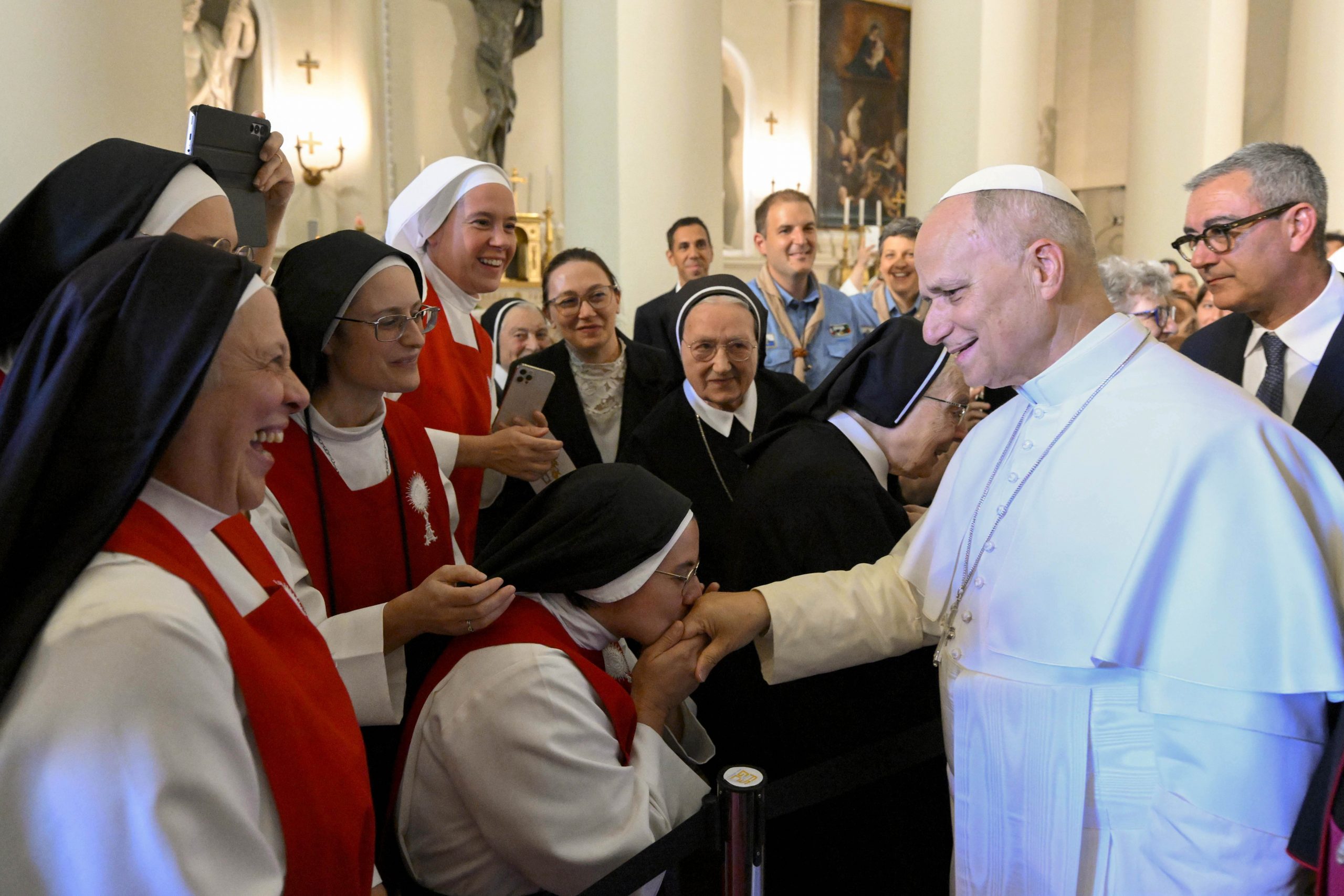 In San Marino, Pope Leo XIV tells young people: ‘We only find authentic freedom in Jesus Christ’ – #Catholic – In the small landlocked country of San Marino on Aug. 22, Pope Leo XIV called on young people to open "the door of their heart" to God, assuring them that the faithful “only find authentic freedom in Jesus Christ."After his arrival in San Marino, one of the smallest and oldest republics in the world, and following a meeting with the country’s captains regent, the pope went to the Basilica of San Marino. There, together with priests and the faithful, he worshiped the Blessed Sacrament and venerated the relics of Saint Marinus.
 
 Pope Leo XIV speaks to pilgrims at the Basilica di San Marino, Aug. 22, 2026. | Credit: Vatican Media
 
 “Iʼm glad to meet you in this basilica,” the pope said in a speech after the moment of prayer. “I would like us to live this moment together as a pause in our common path in the footsteps of Christ.”Addressing especially young people, the Holy Father recalled the words spoken by his predecessor Benedict XVI when visiting San Marino in 2011: “Do not stay in the partial, immediate answers […], easier at first and more comfortable, which can give some moments of happiness, of exaltation, of drunkenness, but that do not lead you to the true joy of living.”Benedict XVI had told pilgrims at the time: “Your heart is an open window to infinity!” Addressing the faithful on Aug. 22, Pope Leo said: “Well, dear young people: keep that window open!” “Follow with the gaze of the soul the paths that trace in you the great longings for beauty, goodness and life that you carry in your heart," the pope said.“If you carefully observe their journey and listen to your voice, they will lead you to the top, to meet God, where He seeks and waits for you; and, with his help, your dreams will have the necessary strength to leave a mark on history and improve it,” he added.As a “second call,” the pope said to young people: “Enthusiastically embrace your mission in the world! Do it, first of all, trying to understand what the call is for you, unique for each one, and value its greatness.”“Then, give yourself to him and invest without reservation all the richness of the gifts that God has granted you,” he continued, encouraging them not to be “fear of making demanding decisions, such as marriage, consecration, orderly ministry, professional life or social and political commitment.”The Holy Father also expressed his “sincere gratitude to the priests, catechists and educators,” who “work for the human and Christian growth of young people,” and highlighted their “hidden, but very important” work of helping parents, who are “first responsible for the education of their children in faith.”“The family, in fact, is the first place of formation in the faith, the natural bosom in which the Gospel is learned from childhood and breathed on a daily basis," he said.He encouraged the faithful to establish “an educational pact, so that parents feel involved, rediscover the faith themselves in a new way and have the joy of transmitting to their children the Christian values of which they are custodians.”While warning that “we live in a world wounded by numerous conflicts,” the pope assured the assembly that, in the face of “these disturbing tendencies,” the response of believers “can be no other than to travel the path of the Gospel with an even greater conviction.”Towards the end of his address inside the basilica, the pope encouraged the faithful to live in communion, giving “testimony of unity in our communities: among the parishes and, within them, between pastors and faithful, among the different charisms and ministries.”After concluding the meeting inside the basilica, the Holy Father addressed a greeting to the faithful who were outside and spoke again in a special way the young people present: “Open the door of your heart, always listen to Jesus Christ and never be afraid to listen to what Jesus wants to say to each of you.”“Recognize in yourselves the value of life. The value of your life, of you, who were created by God and are loved by God: your life has a great value for us, for the Church, for your family and for the whole world,” said the pope.This story was originally published by ACI Prensa, EWTN News’ Spanish-language news partner. It has been translated and adapted by EWTN News English.