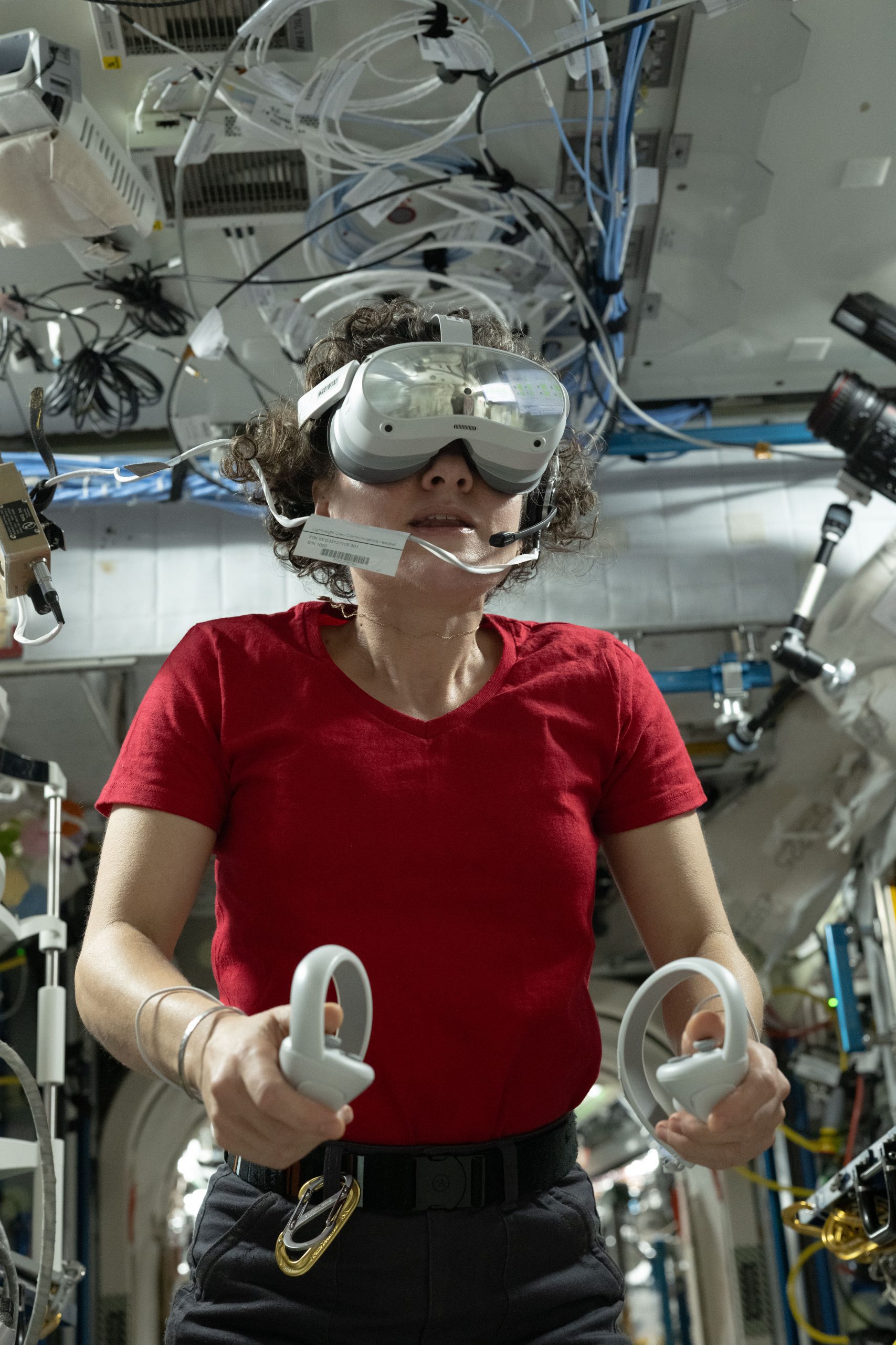 NASA Astronaut Jessica Meir Uses VR Goggles – NASA astronaut and Expedition 75 commander Jessica Meir wears a set of virtual reality goggles, also called the Nevada Screening Vision System, for a test that measures visual function using a series of vision screening apps testing visual acuity, contrast sensitivity, and more. NASA Astronaut Jessica Meir Uses VR Goggles – NASA astronaut and Expedition 75 commander Jessica Meir wears a set of virtual reality goggles, also called the Nevada Screening Vision System, for a test that measures visual function using a series of vision screening apps testing visual acuity, contrast sensitivity, and more.