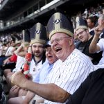 Pope Leo night at White Sox baseball park maxes out stadium capacity #Catholic – CHICAGO (OSV News) — White Sox baseball fans sporting custom-designed black and gold mitre-style hats celebrated Pope Leo XIV, a fellow diehard Sox fan, at a pope-themed game in Chicago Aug. 11.
Dominican Sister Mary Jo Sobieck of Springfield, Illinois, threw the first pitch, and fans shook hands with the “sign of peace,” led by the Chicago Archdiocese’s Father Tom Hurley, during the fifth inning at Rate Field, home of Pope Leo’s favorite baseball team.
White Sox management handed out “pope hats” to over 38,000 fans who showed up at the third game in a series against the Cincinnati Reds. The promo project started out as a fan giveaway for the first 2,500 tickets, which sold quickly and it added another fast-selling 500.
Management expanded the promo to the full stadium capacity and the tickets flew.
“The only anxiety was: Can we get 40,000 here by the time of this day? So as soon as we figured out we could, it’s been a lot of fun to be part of,” Brooks Boyer, White Sox executive vice president, said in a story about the Pope Leo-themed game written for the team’s website.
“We were talking about this before. Is there anything that has rivaled this where we’d have to say, we have to go to 40,000?” he said from the dugout Aug. 11. “We couldn’t remember anything where we’ve had to put it to 40,000.”
Click here to subscribe to our weekly newsletter.
“The place was capacity,” Richard King, a die-hard Sox fan who watched the game on TV, told OSV News.
The game also featured its own familiar penitential rite for Sox fans, as the Reds rallied in the 10th inning to beat the White Sox 5-4, giving Cincinnati a lead in the three-game series that concludes Aug. 13. However, the Sox still lead the American League Central Division.
King, 78, grew up on Chicago’s Southside and has been following his team since he was seven. King, a daily Massgoer and a member of the Knights of Columbus, said the fifth inning “sign of peace” and having Catholicism so openly on display was “great!” He expected the event would raise interest and more curiosity about the Catholic faith.
“Very excited about Pope Night, and obviously a lot of people are excited about it,” White Sox manager Will Venable said in the Sox website story. “Any time we get to celebrate the pope and his fandom of the White Sox is something that we’ll lean into.”
Pope Leo, a Chicago native who grew up in Dolton, Illinois, a south suburb, has been pictured sporting a White Sox baseball cap at the Vatican, and has received multiple Sox-themed presents since his election as pontiff in May 2024.
The pope being a close follower of the Sox made him an instant hit in the Chicago area and across the country, where people have mentioned how relatable he is. Video footage of then-Father Bob Prevost attending Game 1 of the White Sox 2005 World Series match against the Houston Astros went viral. The Sox swept the Astros 4-0 in the series, ending an 88-year drought famously known as the “Curse of the Black Sox.”
A thanksgiving Mass for the pope’s election led by Chicago Cardinal Blase J. Cupich was held at Rate Field a month after the conclave.
In the months that followed Pope Leo’s election, the ballpark was outfitted with papal reminders including a mural of the pope at the entrance to the section where he sat during the World Series matchup and markers on the chair he sat in. Then, a major shareholder of the White Sox told the media the pope told him “he’d love to” throw the first pitch in a new stadium — “schedule permitting” — that is being envisioned for the team’s future.
Chicago White Sox Charities, the team’s philanthropic arm, gave the Augustinians — Pope Leo’s religious order — a ,000 donation on the Pope Leo-themed night. Father Tom McCarthy and Brother David Relstab, the prior provincial and vocations director respectively of the Augustinians’ Midwest province, accepted the gift on the ballfield.
Simone Orendain is an OSV News correspondent. She writes from Chicago.
Pope Leo night at White Sox baseball park maxes out stadium capacity #Catholic – CHICAGO (OSV News) — White Sox baseball fans sporting custom-designed black and gold mitre-style hats celebrated Pope Leo XIV, a fellow diehard Sox fan, at a pope-themed game in Chicago Aug. 11.
Dominican Sister Mary Jo Sobieck of Springfield, Illinois, threw the first pitch, and fans shook hands with the “sign of peace,” led by the Chicago Archdiocese’s Father Tom Hurley, during the fifth inning at Rate Field, home of Pope Leo’s favorite baseball team.
White Sox management handed out “pope hats” to over 38,000 fans who showed up at the third game in a series against the Cincinnati Reds. The promo project started out as a fan giveaway for the first 2,500 tickets, which sold quickly and it added another fast-selling 500.
Management expanded the promo to the full stadium capacity and the tickets flew.
“The only anxiety was: Can we get 40,000 here by the time of this day? So as soon as we figured out we could, it’s been a lot of fun to be part of,” Brooks Boyer, White Sox executive vice president, said in a story about the Pope Leo-themed game written for the team’s website.
“We were talking about this before. Is there anything that has rivaled this where we’d have to say, we have to go to 40,000?” he said from the dugout Aug. 11. “We couldn’t remember anything where we’ve had to put it to 40,000.”
Click here to subscribe to our weekly newsletter.
“The place was capacity,” Richard King, a die-hard Sox fan who watched the game on TV, told OSV News.
The game also featured its own familiar penitential rite for Sox fans, as the Reds rallied in the 10th inning to beat the White Sox 5-4, giving Cincinnati a lead in the three-game series that concludes Aug. 13. However, the Sox still lead the American League Central Division.
King, 78, grew up on Chicago’s Southside and has been following his team since he was seven. King, a daily Massgoer and a member of the Knights of Columbus, said the fifth inning “sign of peace” and having Catholicism so openly on display was “great!” He expected the event would raise interest and more curiosity about the Catholic faith.
“Very excited about Pope Night, and obviously a lot of people are excited about it,” White Sox manager Will Venable said in the Sox website story. “Any time we get to celebrate the pope and his fandom of the White Sox is something that we’ll lean into.”
Pope Leo, a Chicago native who grew up in Dolton, Illinois, a south suburb, has been pictured sporting a White Sox baseball cap at the Vatican, and has received multiple Sox-themed presents since his election as pontiff in May 2024.
The pope being a close follower of the Sox made him an instant hit in the Chicago area and across the country, where people have mentioned how relatable he is. Video footage of then-Father Bob Prevost attending Game 1 of the White Sox 2005 World Series match against the Houston Astros went viral. The Sox swept the Astros 4-0 in the series, ending an 88-year drought famously known as the “Curse of the Black Sox.”
A thanksgiving Mass for the pope’s election led by Chicago Cardinal Blase J. Cupich was held at Rate Field a month after the conclave.
In the months that followed Pope Leo’s election, the ballpark was outfitted with papal reminders including a mural of the pope at the entrance to the section where he sat during the World Series matchup and markers on the chair he sat in. Then, a major shareholder of the White Sox told the media the pope told him “he’d love to” throw the first pitch in a new stadium — “schedule permitting” — that is being envisioned for the team’s future.
Chicago White Sox Charities, the team’s philanthropic arm, gave the Augustinians — Pope Leo’s religious order — a ,000 donation on the Pope Leo-themed night. Father Tom McCarthy and Brother David Relstab, the prior provincial and vocations director respectively of the Augustinians’ Midwest province, accepted the gift on the ballfield.
Simone Orendain is an OSV News correspondent. She writes from Chicago.