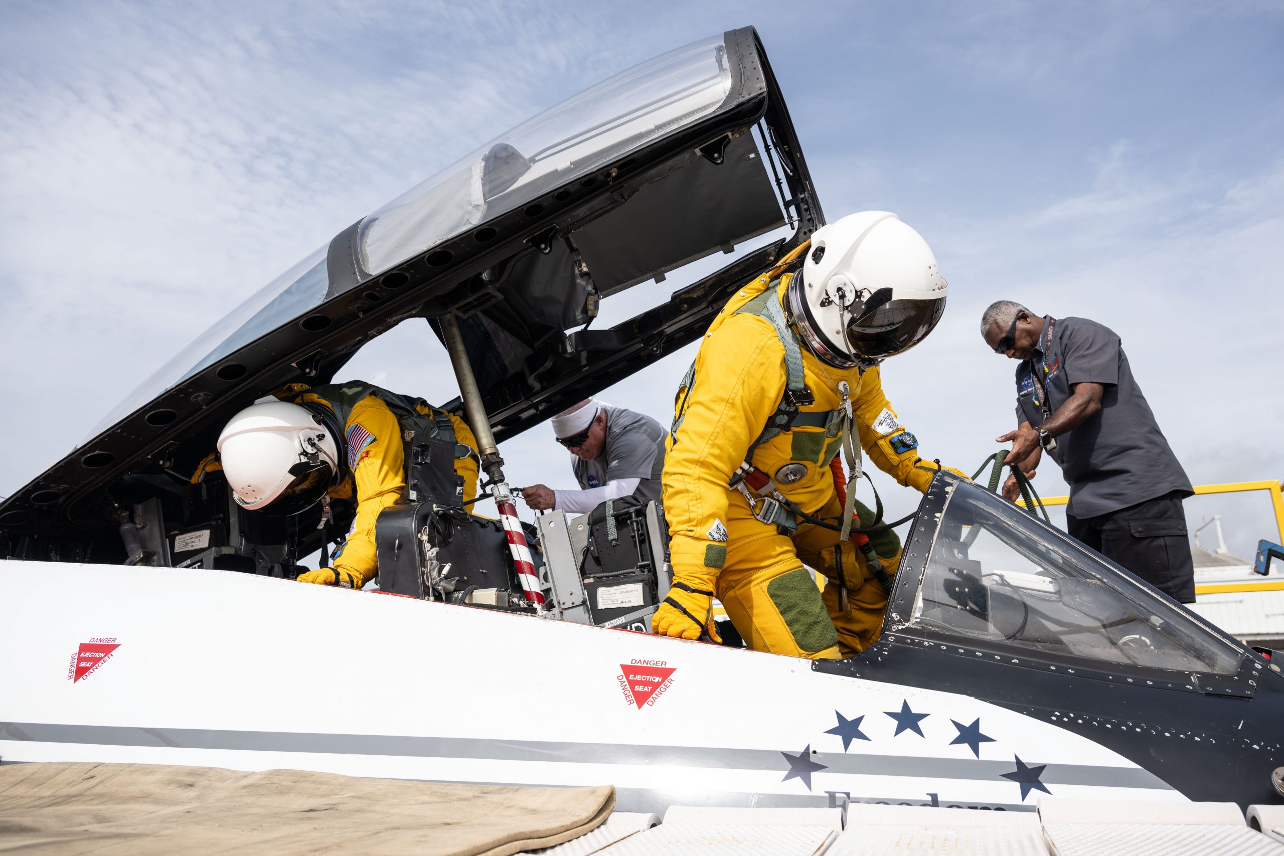 Taking Flight to Prepare for Space – NASA astronaut candidate Adam Fuhrmann prepares for a training flight aboard NASA’s WB-57 aircraft.