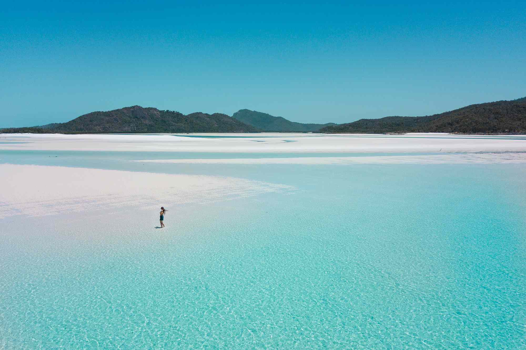 This Australian Beach Is One of the Most Beautiful in the World, With 98 Percent Silica Sand #Travel The pristine white sand on Whitehaven Beach in Queensland is never too hot to walk across.