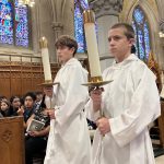 A dream, strong faith and a health struggle inspire teen’s winning essay on priesthood #Catholic – NEWARK, N.J. (OSV News) — Dominic Auricchio was 4 when he said he heard God’s voice in a dream telling him to become a priest.
The now-13-year-old does not remember the dream too well, but he has felt drawn to the Catholic priesthood ever since.
That dream, his strong faith and a struggle with a life-threatening health issue in recent months inspired his winning essay on the priesthood.
When Dominic decided to enter the Archdiocese of Newark’s Cardinal Joseph Tobin Essay and Video Contest — which asks seventh graders to explain why priests are important — he knew exactly what to say: Priests are important because they share God’s Word, celebrate the sacraments, and love everyone as Jesus did.
The archdiocesan Office of Priestly Vocations, which administers the contest, said the judges stated Dominic’s work stood out among the 49 submissions they reviewed. He won first place, receiving a plaque and ,500, presented to him this summer by Father Patrick Seo, director of priestly vocations, at a gathering attended by family and classmates.
“I was really happy when I won,” Dominic told Jersey Catholic, Newark’s archdiocesan news outlet. “Becoming a priest is important to me, so I worked hard on everything. Accepting the award in front of so many people made me feel very accomplished.”

Click here to subscribe to our weekly newsletter.

Dominic’s achievement came during a particularly trying time in his life. In December, he began experiencing seizures for which he is still seeking treatment. In fact, when he first learned about the contest, he was in the hospital.
Despite these struggles, Dominic was determined to do his best, writing and polishing his essay over a few weeks until he was sure every one of his 642 words conveyed his admiration for the priesthood. He even drew on his health issues to offer a unique perspective on the subject.
“(My medical problems) helped me understand how other people feel when they are scared, different, or going through something difficult,” Dominic wrote. “Because of this, I feel called to help people who are hurting. … A priest walks with people during sickness, grief and fear, and I want to be someone who brings comfort and hope.”
As required by the contest, Dominic, with the help of his mother, Maria, and brother Vincenzo, also crafted a four-minute video in which he shared that he was 9 years old when a mass developed on his brain.
While his doctors and parents contemplated the best treatment options, he says he experienced an apparition. Dominic believes that the woman who appeared in his bedroom, wearing blue and a head covering, was the Virgin Mary.
According to Dominic, she told him not to worry and that everything would be OK. Soon thereafter, a CAT scan revealed that his brain mass had begun to shrink.
Today, Dominic’s mass has shrunk to a tiny size. While his recovery cannot be confirmed as miraculous — because he was taking medication that may have caused the improvement — Maria believes God healed her son. She said the mass began shrinking immediately after Mary’s visit, a timing she believes is too remarkable to be mere coincidence.
Dominic, too, believes that something more than medicine was at work. He also feels fortunate to be able to share his experience with the world.
“I like telling other people because it reminds them that God is always there,” Dominic said. “It gives them hope.”
In his essay, he also explained how his time as an altar server at St. Helen’s Parish in Westfield has brought him close to the Eucharist and helped him “see how important the priest’s role is.”
He also talks about experiences such as giving alms during Lent and serving as a “buddy” to a young girl with autism during St. Helen’s inclusive Masses, which have taught him “patience and kindness,” qualities he believes all priests should possess.
“I think a priest should always make people feel like they belong,” Dominic wrote in his essay.
His pastor, Msgr. Thomas Nydegger, said that Dominic certainly possesses the empathy that is an essential quality of priests.
“From what I’ve seen of Dominic and the way he lives, he’d bring some very special gifts and talents to the priesthood,” Msgr. Nydegger said. “With his sensitivity and unique perspective, I think he’d be able to truly touch people’s lives in a deep way that we don’t often see in the world.”
Maria — who works in multiple roles at St. Helen Parish and Holy Trinity School — said she would feel “honored” to be the mother of a priest. At the same time, she said her son is the only one who can decide whether the priesthood is right for him. She has told him he should not feel obligated to become a priest if he ever changes his mind.
“I just want him to be happy and find where God is calling him to be,” said Maria, who noted that there are many ways to serve God.
Dominic, who also loves hockey and hopes to one day follow in his father’s and great-grandfather’s footsteps by enlisting in the Marines, wrote in his essay that “I do not know exactly where God will lead me, but I trust that He is guiding me step by step.”
Still, he strongly feels that he will ultimately fulfill his dream of becoming a priest.
“The Roman Catholic priesthood is a life of service, sacrifice, and joy centered on Jesus,” he writes. “That is why I believe God is calling me to become a priest, and why I hope to answer that call one day.”
Sean Quinn is on the communications staff of the Archdiocese of Newark and contributes to Jersey Catholic, the archdiocese’s news site.
&nbsp;