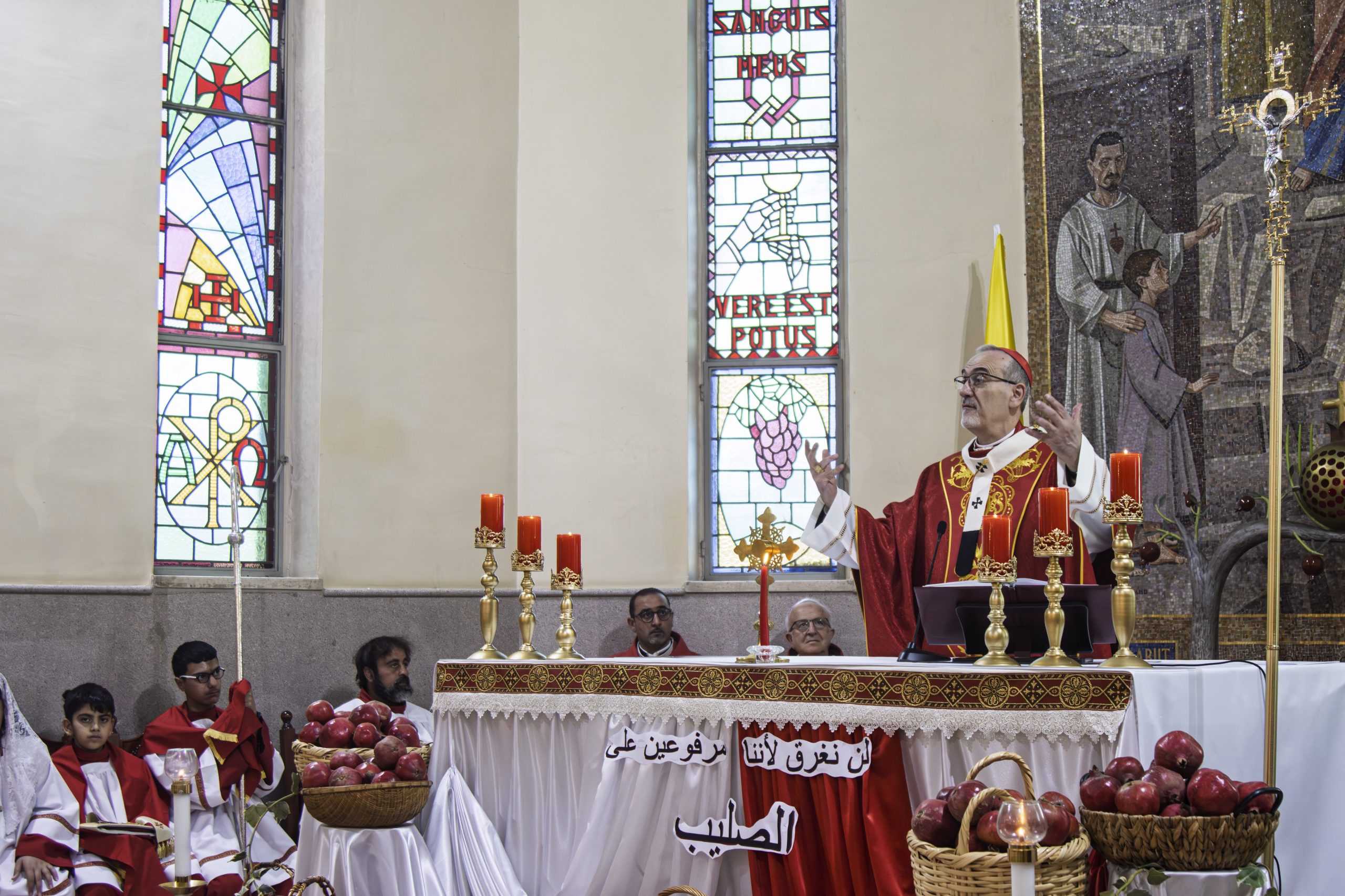 Cardinal Pizzaballa calls Christians in the Holy Land to make the cross a way of life #Catholic Cardinal Pierbattista Pizzaballa, the Latin patriarch of Jerusalem, said the cross is not a sign of defeat or death but an expression of God’s love and the victory of life, urging Christians in the Holy Land to make it a way of life rooted in love and self-giving.
 
 Cardinal Pierbattista Pizzaballa presides over Mass on the eve of the feast of the Exaltation of the Holy Cross at Christ the Redeemer Church in Taybeh, West Bank, Sept. 13, 2026. | Credit: Emad Diab/ACI MENA
 
 Pizzaballa made the remarks while presiding over a Mass on the eve of the feast of the Exaltation of the Holy Cross at Christ the Redeemer Church in Taybeh, a predominantly Christian town in the West Bank.Bishop William Shomali, patriarchal vicar; Father Davide Meli; and Father Bashar Fawadleh, the parish priest, concelebrated the Mass.“The cross is our victory, and it is the victory of love,” Pizzaballa said. He added that Christ “chose to enter into the suffering of the cross out of love for us.” The patriarch stressed that Christians are “people of the cross” and that the sign defining their identity should be reflected in the way they live and in their relationships within their families, parishes, and wider communities.“We are called to live according to the logic of the cross,” he said.Pizzaballa noted that Christians do not need to seek out suffering, because they are already surrounded by suffering in many forms. Yet, he said, such experiences can become an opening for God’s presence in their lives.Fawadleh welcomed Pizzaballa to the celebration, telling him: “Your presence today is more than simply taking part in our feast; it is a sign of communion, consolation, and hope.”
 
 Cardinal Pierbattista Pizzaballa lights the flame at the historic St. George Church, locally known as Al-Khader, Sept. 13, 2026, at Christ the Redeemer Church in Taybeh, West Bank. | Credit: Emad Diab/ACI MENA
 
 The celebration took place as Taybeh continues to face the repercussions of attacks by Israeli settlers, restrictions on movement and access to essential services (Palestinians living in the West Bank require Israeli permits to enter Jerusalem), declining employment opportunities, and continued emigration — all pressures that have placed additional strain on the town’s residents.Following the Mass, the faithful joined a candlelight procession through the streets of Taybeh to the historic St. George Church, known locally as Al-Khader. There, prayers were offered and pomegranates were blessed and distributed to participants before the traditional feast day flame was lit.This story was first published by ACI MENA, the Arabic-language sister service of EWTN News. It has been translated and adapted by EWTN News English.