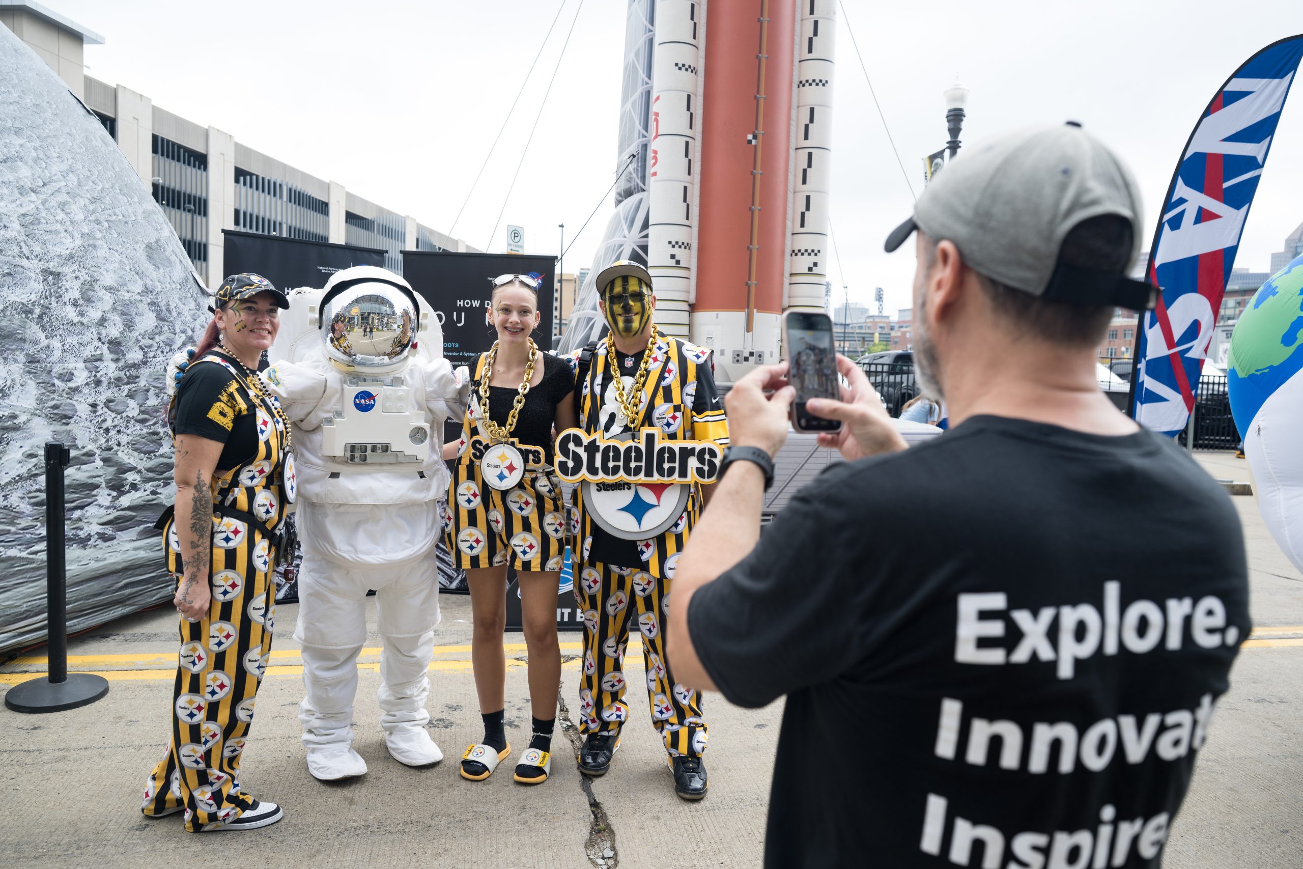NASA Kicks Off Inspiration Tour with Steelers vs. Falcons Game – Fans pose for a photo with an astronaut in the NASA Experience Zone at an NFL game between the Pittsburgh Steelers and the Atlanta Falcons at Acrisure Stadium, Sunday, Sept. 13, 2026, in Pittsburgh, Pennsylvania.
