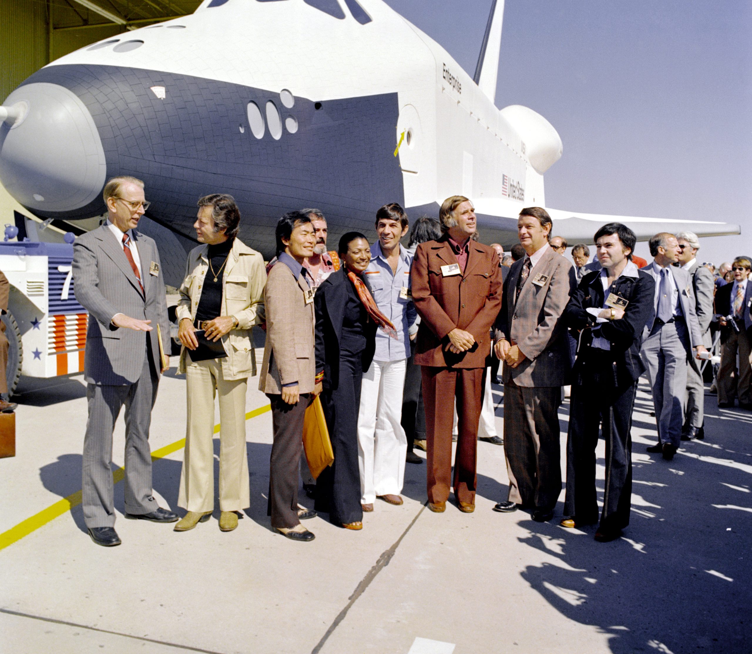 NASA Unveils Enterprise, the First Space Shuttle – The rollout ceremony for NASA’s first space shuttle, OV-101, coincided with Constitution Day of the nation’s bicentennial on Sept.17, 1976. Although the orbiter was originally planned to be named Constitution, Star Trek fans successfully convinced President Gerald Ford to name it Enterprise after the series’ fictional starship. NASA Unveils Enterprise, the First Space Shuttle – The rollout ceremony for NASA’s first space shuttle, OV-101, coincided with Constitution Day of the nation’s bicentennial on Sept.17, 1976. Although the orbiter was originally planned to be named Constitution, Star Trek fans successfully convinced President Gerald Ford to name it Enterprise after the series’ fictional starship.