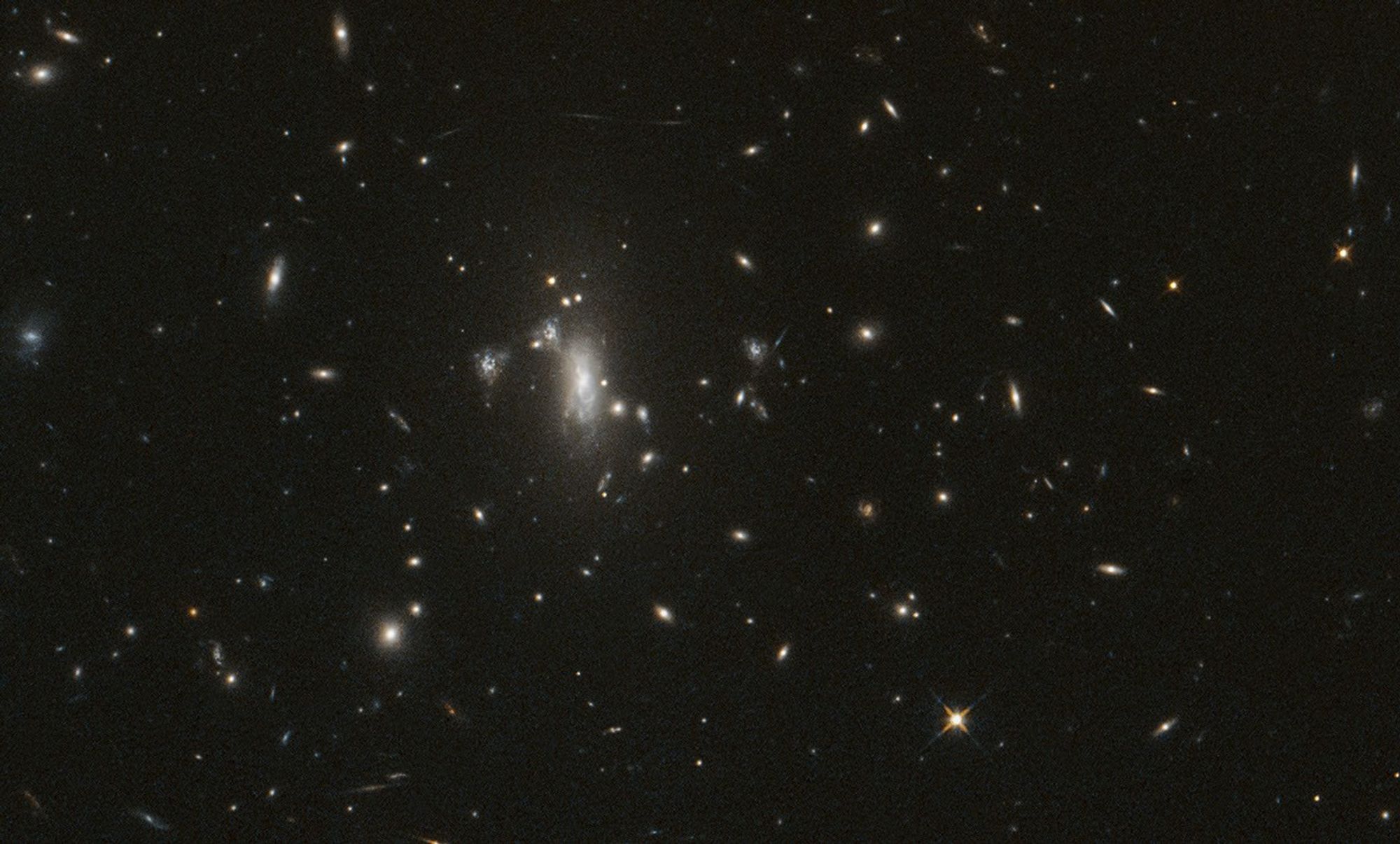 NASA’s Hubble Telescope Reaches Milestone, Looks for Elusive Supernova – An image from NASA’s Hubble Space Telescope of galaxy cluster MACS J0417 is part of repeated observations to monitor for the reappearance of supernova Athena, which can help astronomers measure the expansion rate of the universe.