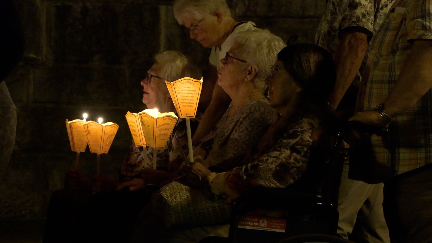 Over 150,000 visitors prepare to welcome Pope Leo in Lourdes #Catholic LOURDES, France — As Pope Leo XIV lands in Paris to begin the first official papal visit to France since 2008, pilgrims, organizers, and business owners in Lourdes are preparing for his arrival in the town expected on Saturday night.Patrick Vinuales, owner of Hôtels Vinuales — the largest hotel chain in Lourdes — told EWTN News: “The average number of people who would be staying in Lourdes is roughly 20,000. But for the Sunday Mass, there will be something like 150,000 people. We expect altogether an attendance of nearly a quarter of a million people over the weekend.”“What I think is very important is the enthusiasm of people. A lot of people have been calling us saying even if they couldnʼt come, they were so happy for the pope to come to Lourdes, to reveal more about the message of Our Lady to Bernadette,” he told EWTN News.Tourism is a big business in Lourdes. The town is widely considered to be the area with the highest concentration of hotels in France outside of Paris — rather unusual for a town with a population of 10,000. Hotel owners have been making the most of the increase in numbers.Joseph Tedesco, owner of the Grand Hôtel Moderne, built in 1896 by the nephew of St. Bernadette, told EWTN News: “Everybody increased their prices… We made a huge effort to welcome individuals, because usually itʼs mostly big dioceses… but this event made more individuals come and thatʼs a completely different type of business.”For the major ceremonies, tourists will need to have registered in advance, or they won’t be allowed into the sanctuary. “The biggest challenge is the people who organized the pilgrimage before they knew the pope was coming. There are a lot of people who donʼt have their ticket,” he said. “Our hotel is in the red area, so it wonʼt be accessible [by car].”Pope John Paul II visited Lourdes in 1983 and 2004. In 2007, Pope Benedict XVI visited, which Tedesco recalls. “Two months after I bought the hotel 18 years ago, Pope Benedict XVI arrived… We didnʼt have all this security for sure. But thatʼs maybe because we didnʼt have the geopolitical problem that we have today.”
 
 Pilgrims gather to pray before Pope Leo arrives in Lourdes, France, during his papal trip to France Sept. 25-28, 2026. | Credit: Elliot Hartley
 
 “This visit is, first and foremost, a visit by the Successor of Peter to strengthen his brothers in the faith and to address our society as a whole,” said Monsignor Jean-Marc Micas, bishop of Tarbes and Lourdes.During this visit, Pope Leo will pray at the grotto and take part in the torchlight procession, meet with bishops of the French Episcopal Conference, celebrate Holy Mass, and meet the staff and sick community at Accueil Notre Dame, the main hospital for sick pilgrims.He also will meet privately with seven survivors of sexual abuse in the Church — a major focus for critics who argue the Church hasn’t confronted the problem fully.The visit also marks an increase in the number of attendees on organized pilgrimage groups. Most visitors to Lourdes come as part of an organized group, often with their local diocese.Caroline Trainor, a Lourdes organizer for Joe Walsh Tours, told EWTN News she had seen a huge increase in sign-ups. “When they heard that the pope was visiting, they were signing up to come back to be here over the weekend,” she said. “So thatʼs really positive for the future because it brings Lourdes back into the spotlight… Even coming in this morning, you can kind of feel this little ripple of excitement.”Lourdes’ story can be traced back to 1858, when St. Bernadette Soubirous, a 14-year-old peasant girl, had apparitions of Our Lady in a small cave. A shrine was built there, and the Pyrenean town became a pilgrimage site known for its miraculous healings.Paul Eaton, president of Ireland’s national Carmelite pilgrimage, told EWTN News: “It’s just electrifying. You really have to come here to experience it. It’s just something else… weʼre so blessed to have this honor.”“When the news first came out, we thought ‘this is not happening!’ That increased our numbers, which was fantastic… Weʼre very lucky because we have an awful lot of the same people that come with us every year who are actually hooked… They love Lourdes. They really, really do.”Michael Murphy has been coming on pilgrimage to Lourdes for 19 years. He told EWTN News: “Thereʼs a draw that continually brings me back. Itʼs difficult to explain. Itʼs just the serenity and the atmosphere. For the dates and to align with the pope as well, it just made it extra special.”Organized pilgrimages to Lourdes often have two sides. Pilgrims can either join as someone in need of assistance or as a volunteer. Those with learning or physical disabilities spend the week being assisted by volunteers, who help them with their daily needs.Clíona, a first-time pilgrim, told EWTN News: “I heard people describing Lourdes before, but I never expected it just to be like this. Thereʼs something about it. Itʼs like a magical place.”“Itʼs a different experience than Iʼve ever experienced before,” Harry Lynch, another first-time pilgrim, told EWTN News. “I wasnʼt expecting it to be this busy. Everyoneʼs very excited about everything thatʼs about to happen.”Martin has been visiting Lourdes for 20 years from Ireland. He told EWTN News: “Weʼve got more youth coming now than we had years ago, which is great. With the visit of the pope, we’re getting two trips in one! Thereʼs so much excitement, so much talk about it, and itʼs a great thing for everyone. Some people donʼt get the chance to go to Rome, so they’re getting a real run for their money this year.”The visit is expected to provide a huge boost to Lourdes’ economy. Natasha Afonso, a local souvenir shop owner, told EWTN News: “When tourists found out the pope was coming, many delayed their trips to align the dates. So, we lost a lot of business in the middle [of the] season, but now it’s growing again.”“Lourdes is known for its miracles, so it’s good for the publicity, for the young people, and the new generations to come.”