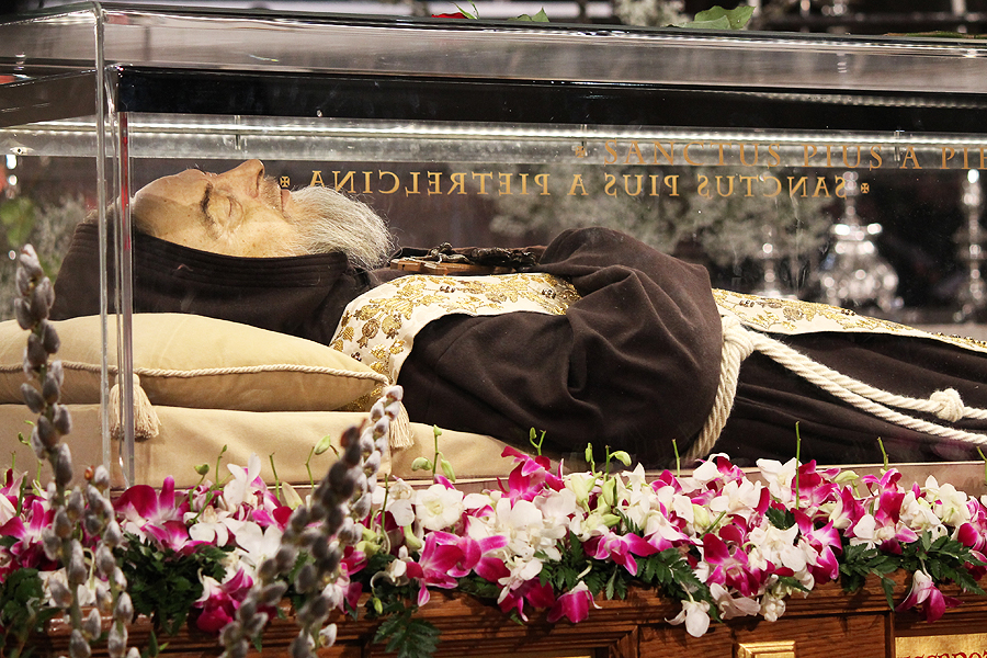 Padre Pio: 13 facts about St. Pio of Pietrelcina to know and share – #Catholic – One of the most popular Catholic saints of the 20th century, St. Pio of Pietrelcina, commonly known as Padre Pio, was a Capuchin Franciscan friar, priest, and mystic. His tomb can be found in the Sanctuary of St. Mary Our Lady of Grace in San Giovanni Rotondo, Italy.Padre Pio is known for his deep wisdom about prayer and peace, his stigmata, miraculous reports of his bilocation, being physically attacked by the devil, and mastering the spiritual life.As the Church celebrates his feast day on Sept. 23, here’s a look at 13 facts about St. Pio’s life and faith.1. Padre Pio was only 5 years old when he expressed a strong desire to serve God.Born Francesco Forgione on May 25, 1887, in Pietrelcina, Italy, he served as an altar boy at his local parish. At the early age of 5, he consecrated himself to Jesus. By the age of 10, his family looked to see how he could become a Capuchin friar.2. Padre Pio was only 15 when he entered the Capuchin Friars Minor as a novice.Being a young teenager, Francesco was given the name Pio or Pius when he entered as a novice. He professed his solemn vows three years later. No stranger to suffering amid frail health throughout much of his studies, he was ordained a priest in 1910. He ascended the Gargano mountains to the rural friary outside of San Giovanni Rotondo in 1916. He remained there for more than 50 years, until his death on Sept. 23, 1968.3. St. Pio received the visible wounds of Christ known as the stigmata, just like St. Francis of Assisi.On Sept. 20, 1918, Padre Pio received the stigmata while praying in a church. The wounds remained visible on his body for the rest of his life. The wounds were on his hands, feet, and side, corresponding to the wounds suffered by Jesus during his crucifixion.4. The blood from his stigmata smelled of floral perfume.Referred to as the “odor of sanctity,” the blood that came from Padre Pio’s wounds is said to have smelled like perfume or as having a floral aroma. The trait has also been exhibited by other saints who manifested stigmata markings.5. Padre Pio heard confessions 12 to 15 hours a day.While listening to confessions, the saint would smell flowers as sins were confessed. Some penitents waited two weeks just to visit him in the confessional. Padre Pio could also read the hearts of penitents, reminding them of sins that were forgotten or omitted.The saint once said: “Confession is the soul’s bath. You must go at least once a week. I do not want souls to stay away from confession more than a week. Even a clean and unoccupied room gathers dust; return after a week, and you will see that it needs dusting again!”6. Padre Pio suffered attacks from the devil on a consistent basis.From a young age, Padre Pio was blessed with heavenly visions, but he also experienced spiritual warfare, including attacks of the devil. In a book written by Father Gabriele Amorth on Padre Pio, the famous exorcist of Rome said: “The great and constant struggle in the life of the saint was against the enemies of God and souls, those demons who sought to capture his soul.”Amorth continued: “The devil appeared to him under many different forms: as a big black cat, wild and threatening, or as a repulsive animal, in the clear intention to frighten him; under the appearance of naked and provocative young girls who danced obscene dances, obviously to test the chastity of the young priest. However, the worst was when the devil took on the appearance of his spiritual director, or posed as Jesus, the Virgin Mary, or St. Francis.”7. He had the gift of bilocation, meaning that he could be in more than one place at a time.Multiple eyewitness accounts attest to the ability of Padre Pio to be in multiple places at once. Fellow friars remember seeing him in prayer outside when they knew he was still in his room. Some accounts come from others who claim to have seen him on different continents all over the world.As to how Padre Pio experienced such feats, the closest he ever came to an explanation of bilocation was to say that it occurred “by an extension of his personality.”8. A sighting of a “flying friar” kept war planes from bombing Padre Pio’s town during World War II.Among the most remarkable of the documented cases of bilocation was Padre Pio’s appearance in the air over San Giovanni Rotondo during World War II. While southern Italy remained in Nazi hands, American bombers were given the job of attacking the city of San Giovanni Rotondo. However, when they appeared over the city and prepared to unload their munitions, a brown-robed friar appeared before their aircraft. All attempts to release the bombs failed. In this way, Padre Pio kept his promise to the citizens that their town would be spared. Later on, when an American airbase was established at Foggia a few miles away, one of the pilots of the incident visited the friary and found, to his surprise, the friar he had seen in the air that day over San Giovanni.9. Before dying at the age of 81, all his wounds healed without scars, just as he had foretold they would 50 years prior.A doctor examining the saint’s body who was present when he was dying observed that the wounds of the stigmata were completely healed, without any trace or scar. Padre Pio’s body was placed in a coffin in the church of the monastery to allow pilgrims to visit and pray.10. Pilgrims can visit the rooms in which Padre Pio lived.All the cells where Padre Pio lived in Italy have been outfitted with vintage furnishings to make them look exactly like they were in the early 20th century. Each site also boasts a small museum with relics and artifacts from his life.11. Many miracles have been attributed to Padre Pio.Several miracles have been attributed to the saint’s intercession, including the story of Gemma di Giorgio, a little girl who visited Padre Pio. Born blind without pupils in either eye, she miraculously regained her sight after visiting him. One truly miraculous factor about her healing was that, although she could see, she still lacked pupils. Another miracle was chronicled on EWTN.12. He established a hospital.Living a life of suffering, made difficult by physical pain and sickness, Padre Pio was able to build a hospital with the help of generous sponsors. Casa Sollievo della Sofferenza, which means “Home for the Relief of the Suffering,” was inaugurated on May 5, 1956. The hospital sits atop a hill overlooking San Giovanni Rotondo. Starting with only about 250 beds and just enough equipment, the hospital is now known for its state-of-the-art facilities and services.13. Even before his death on Sept. 23, 1968, Padre Pio reportedly spent his last moments in prayer.Beatified in 1999, St. Padre Pio was canonized on June 16, 2002, by the late St. John Paul II. He is known among Catholics as St. Pio of Pietrelcina. More than 500,000 attended his canonization. He celebrated Mass the day before his death.This story was first published by the National Catholic Register, the sister partner of EWTN News, and has been adapted and updated by EWTN News. Padre Pio: 13 facts about St. Pio of Pietrelcina to know and share – #Catholic – One of the most popular Catholic saints of the 20th century, St. Pio of Pietrelcina, commonly known as Padre Pio, was a Capuchin Franciscan friar, priest, and mystic. His tomb can be found in the Sanctuary of St. Mary Our Lady of Grace in San Giovanni Rotondo, Italy.Padre Pio is known for his deep wisdom about prayer and peace, his stigmata, miraculous reports of his bilocation, being physically attacked by the devil, and mastering the spiritual life.As the Church celebrates his feast day on Sept. 23, here’s a look at 13 facts about St. Pio’s life and faith.1. Padre Pio was only 5 years old when he expressed a strong desire to serve God.Born Francesco Forgione on May 25, 1887, in Pietrelcina, Italy, he served as an altar boy at his local parish. At the early age of 5, he consecrated himself to Jesus. By the age of 10, his family looked to see how he could become a Capuchin friar.2. Padre Pio was only 15 when he entered the Capuchin Friars Minor as a novice.Being a young teenager, Francesco was given the name Pio or Pius when he entered as a novice. He professed his solemn vows three years later. No stranger to suffering amid frail health throughout much of his studies, he was ordained a priest in 1910. He ascended the Gargano mountains to the rural friary outside of San Giovanni Rotondo in 1916. He remained there for more than 50 years, until his death on Sept. 23, 1968.3. St. Pio received the visible wounds of Christ known as the stigmata, just like St. Francis of Assisi.On Sept. 20, 1918, Padre Pio received the stigmata while praying in a church. The wounds remained visible on his body for the rest of his life. The wounds were on his hands, feet, and side, corresponding to the wounds suffered by Jesus during his crucifixion.4. The blood from his stigmata smelled of floral perfume.Referred to as the “odor of sanctity,” the blood that came from Padre Pio’s wounds is said to have smelled like perfume or as having a floral aroma. The trait has also been exhibited by other saints who manifested stigmata markings.5. Padre Pio heard confessions 12 to 15 hours a day.While listening to confessions, the saint would smell flowers as sins were confessed. Some penitents waited two weeks just to visit him in the confessional. Padre Pio could also read the hearts of penitents, reminding them of sins that were forgotten or omitted.The saint once said: “Confession is the soul’s bath. You must go at least once a week. I do not want souls to stay away from confession more than a week. Even a clean and unoccupied room gathers dust; return after a week, and you will see that it needs dusting again!”6. Padre Pio suffered attacks from the devil on a consistent basis.From a young age, Padre Pio was blessed with heavenly visions, but he also experienced spiritual warfare, including attacks of the devil. In a book written by Father Gabriele Amorth on Padre Pio, the famous exorcist of Rome said: “The great and constant struggle in the life of the saint was against the enemies of God and souls, those demons who sought to capture his soul.”Amorth continued: “The devil appeared to him under many different forms: as a big black cat, wild and threatening, or as a repulsive animal, in the clear intention to frighten him; under the appearance of naked and provocative young girls who danced obscene dances, obviously to test the chastity of the young priest. However, the worst was when the devil took on the appearance of his spiritual director, or posed as Jesus, the Virgin Mary, or St. Francis.”7. He had the gift of bilocation, meaning that he could be in more than one place at a time.Multiple eyewitness accounts attest to the ability of Padre Pio to be in multiple places at once. Fellow friars remember seeing him in prayer outside when they knew he was still in his room. Some accounts come from others who claim to have seen him on different continents all over the world.As to how Padre Pio experienced such feats, the closest he ever came to an explanation of bilocation was to say that it occurred “by an extension of his personality.”8. A sighting of a “flying friar” kept war planes from bombing Padre Pio’s town during World War II.Among the most remarkable of the documented cases of bilocation was Padre Pio’s appearance in the air over San Giovanni Rotondo during World War II. While southern Italy remained in Nazi hands, American bombers were given the job of attacking the city of San Giovanni Rotondo. However, when they appeared over the city and prepared to unload their munitions, a brown-robed friar appeared before their aircraft. All attempts to release the bombs failed. In this way, Padre Pio kept his promise to the citizens that their town would be spared. Later on, when an American airbase was established at Foggia a few miles away, one of the pilots of the incident visited the friary and found, to his surprise, the friar he had seen in the air that day over San Giovanni.9. Before dying at the age of 81, all his wounds healed without scars, just as he had foretold they would 50 years prior.A doctor examining the saint’s body who was present when he was dying observed that the wounds of the stigmata were completely healed, without any trace or scar. Padre Pio’s body was placed in a coffin in the church of the monastery to allow pilgrims to visit and pray.10. Pilgrims can visit the rooms in which Padre Pio lived.All the cells where Padre Pio lived in Italy have been outfitted with vintage furnishings to make them look exactly like they were in the early 20th century. Each site also boasts a small museum with relics and artifacts from his life.11. Many miracles have been attributed to Padre Pio.Several miracles have been attributed to the saint’s intercession, including the story of Gemma di Giorgio, a little girl who visited Padre Pio. Born blind without pupils in either eye, she miraculously regained her sight after visiting him. One truly miraculous factor about her healing was that, although she could see, she still lacked pupils. Another miracle was chronicled on EWTN.12. He established a hospital.Living a life of suffering, made difficult by physical pain and sickness, Padre Pio was able to build a hospital with the help of generous sponsors. Casa Sollievo della Sofferenza, which means “Home for the Relief of the Suffering,” was inaugurated on May 5, 1956. The hospital sits atop a hill overlooking San Giovanni Rotondo. Starting with only about 250 beds and just enough equipment, the hospital is now known for its state-of-the-art facilities and services.13. Even before his death on Sept. 23, 1968, Padre Pio reportedly spent his last moments in prayer.Beatified in 1999, St. Padre Pio was canonized on June 16, 2002, by the late St. John Paul II. He is known among Catholics as St. Pio of Pietrelcina. More than 500,000 attended his canonization. He celebrated Mass the day before his death.This story was first published by the National Catholic Register, the sister partner of EWTN News, and has been adapted and updated by EWTN News.