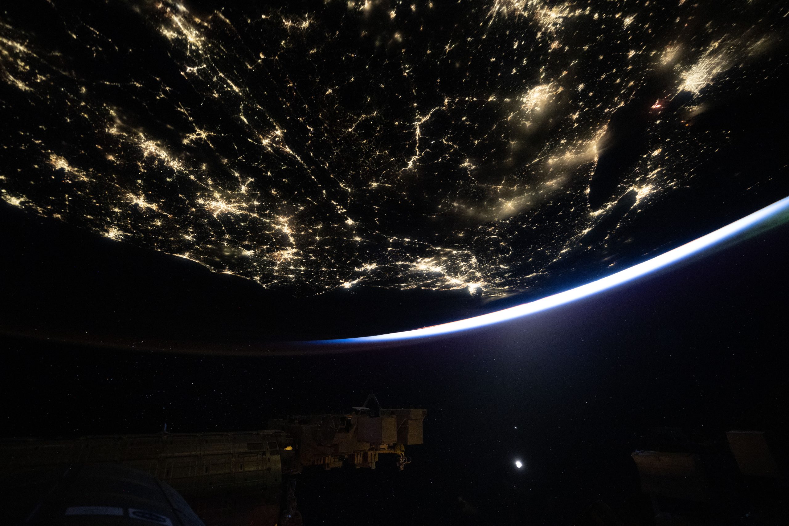 Space Station View of Earth at Night – This nighttime view of the United States, dotted with city lights looking toward New York City (center), was taken at approximately 3:40 a.m. local time from the International Space Station as it orbited 259 miles above Earth. Space Station View of Earth at Night – This nighttime view of the United States, dotted with city lights looking toward New York City (center), was taken at approximately 3:40 a.m. local time from the International Space Station as it orbited 259 miles above Earth.