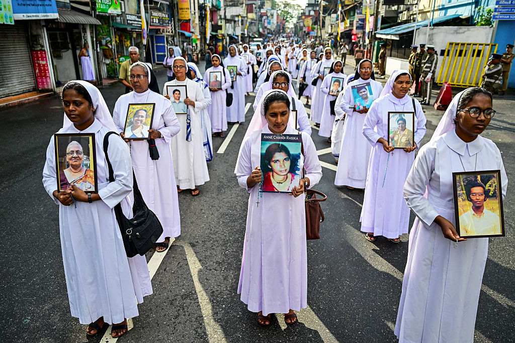 Sri Lanka jails 15 for up to 260 years over Easter Sunday church bombings – #Catholic – Sri Lanka’s High Court has sentenced 15 men to prison terms of 200 to 260 years for their roles in the 2019 Easter Sunday bombings. The convictions are the first directly tied to the attacks on three churches and three hotels that killed 279 people.A three-judge bench in Colombo delivered the verdict Sept. 22 after a nearly five-year trial involving 23,270 charges, LiCAS.news reported. Fourteen defendants were convicted on all counts, including murder, conspiracy to commit terrorism, and possession of firearms and explosives under the Prevention of Terrorism Act. Nine were acquitted, while a 15th was convicted on some counts. The court also ordered the confiscation of the convicts’ property.According to the sentencing list published by Sri Lanka Mirror, one defendant received 260 years, four received 240 years, five received 220 years, and five received 200 years. Prosecutors identified Mohamed Naufar, an Islamist preacher, as the ringleader who supported the suicide bombers, and he received 220 years.The dead included 45 foreign nationals, among them five U.S. citizens, according to the U.S. Justice Department.Father Jude Krishantha Fernando, director of mass communications for the Archdiocese of Colombo, welcomed the ruling but said those convicted “represented only one part of the case,” Newswire reported. He also called for scrutiny of whether intelligence and security officials had enough information to prevent the attacks.“Finally, we have justice,” Fernando told Agence France-Presse. “It has taken a long time to get to this point.”Church presses for a full accountingFor years, the Church has pressed to identify those who ordered the attacks. Cardinal Malcolm Ranjith of Colombo called the 2020 release of several suspects “sad and unfortunate,” and Pope Francis urged Sri Lankan authorities in 2022 to clarify “definitively who was responsible.”In February 2026, police arrested former intelligence chief Suresh Sallay, and the archdiocese asked that the investigation proceed “unhindered from any quarters.” Sallay denies the allegations.In July, former police chief Pujith Jayasundara and former defense secretary Hemasiri Fernando were sentenced to death for failing to act on intelligence warnings. In August, Ranjith said the Church “cannot support capital punishment because it violates human dignity,” Radio Veritas Asia reported.In 2025, the Dicastery for the Causes of Saints added the 167 Catholics killed in the bombings to its list of “Witnesses of Faith.” Sri Lanka jails 15 for up to 260 years over Easter Sunday church bombings – #Catholic – Sri Lanka’s High Court has sentenced 15 men to prison terms of 200 to 260 years for their roles in the 2019 Easter Sunday bombings. The convictions are the first directly tied to the attacks on three churches and three hotels that killed 279 people.A three-judge bench in Colombo delivered the verdict Sept. 22 after a nearly five-year trial involving 23,270 charges, LiCAS.news reported. Fourteen defendants were convicted on all counts, including murder, conspiracy to commit terrorism, and possession of firearms and explosives under the Prevention of Terrorism Act. Nine were acquitted, while a 15th was convicted on some counts. The court also ordered the confiscation of the convicts’ property.According to the sentencing list published by Sri Lanka Mirror, one defendant received 260 years, four received 240 years, five received 220 years, and five received 200 years. Prosecutors identified Mohamed Naufar, an Islamist preacher, as the ringleader who supported the suicide bombers, and he received 220 years.The dead included 45 foreign nationals, among them five U.S. citizens, according to the U.S. Justice Department.Father Jude Krishantha Fernando, director of mass communications for the Archdiocese of Colombo, welcomed the ruling but said those convicted “represented only one part of the case,” Newswire reported. He also called for scrutiny of whether intelligence and security officials had enough information to prevent the attacks.“Finally, we have justice,” Fernando told Agence France-Presse. “It has taken a long time to get to this point.”Church presses for a full accountingFor years, the Church has pressed to identify those who ordered the attacks. Cardinal Malcolm Ranjith of Colombo called the 2020 release of several suspects “sad and unfortunate,” and Pope Francis urged Sri Lankan authorities in 2022 to clarify “definitively who was responsible.”In February 2026, police arrested former intelligence chief Suresh Sallay, and the archdiocese asked that the investigation proceed “unhindered from any quarters.” Sallay denies the allegations.In July, former police chief Pujith Jayasundara and former defense secretary Hemasiri Fernando were sentenced to death for failing to act on intelligence warnings. In August, Ranjith said the Church “cannot support capital punishment because it violates human dignity,” Radio Veritas Asia reported.In 2025, the Dicastery for the Causes of Saints added the 167 Catholics killed in the bombings to its list of “Witnesses of Faith.”