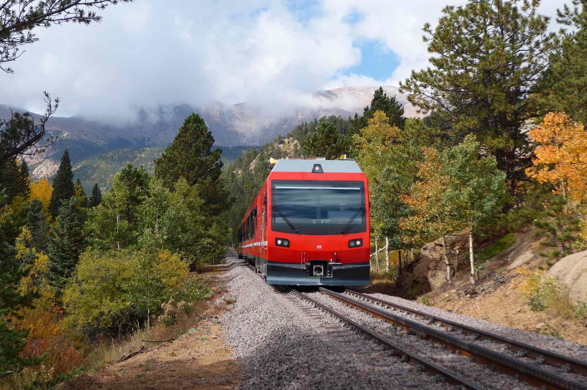 This Colorado Cog Railway Climbs to 14,000 Feet for Epic Mountain Views, Golden Fall Foliage, and Elk Sightings #Travel One of only two of its kind in the U.S., the Pikes Peak route offers breathtaking views of the Rockies.
